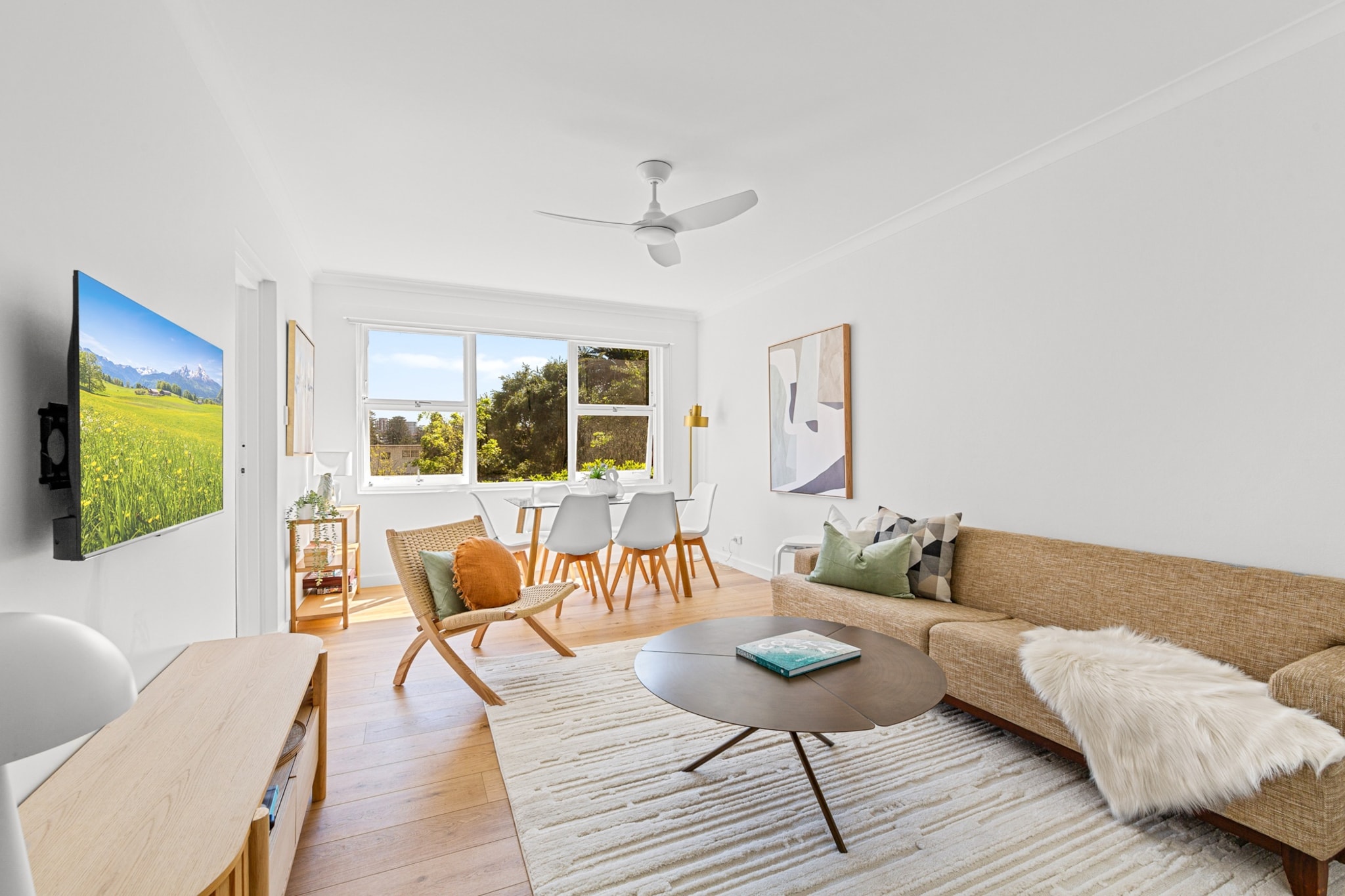 A very short walk to the iconic Manly Beach, this elegant 3-bed apartment features spacious interiors, modern decor, and large windows that fill the space with natural light. With light tones, timber floors and a lovely private balcony, enjoy secure parking, and easy access to Manly Wharf for all public transport and ferry options. Explore the nearby Shelly Beach, Fairlight Beach, and the vibrant café and restaurant scene of this exciting Sydney suburb.
The space
This delightful Manly apartment features spacious and bright interiors with timber floors and light-toned decor that enhance its homely feel. The open-plan living area seamlessly connects to a private undercover balcony with comfortable seating, perfect for relaxing and enjoying the coastal breeze. The three elegantly furnished bedrooms are designed for comfort, while the renovated bathrooms offer a modern touch. Ceiling fans, Wi-Fi, internal laundry and parking will help you feel looked after during your stay. Located just a short walk from Manly Beach & Manly Wharf, you’ll have easy access to the stunning shoreline and the vibrant local dining and shopping scene. Ideal for a relaxed beachside lifestyle, this apartment combines modern amenities with the charm of Manly’s coastal living.
 
Living room
- Couch sits 3 people + additional chair and stools
- TV with streaming options (guests to use their credentials)
 
Kitchen & Dining Area
- Fully equipped with utensils and cutlery
- Electric oven stovetop
- Dining area sits 6 people
 
Bathroom & Laundry
- 1 full bathroom & 1 WC
- Laundry room available with washer and dryer
- Travel essentials, towels and hairdryer provided
 
Amenity Notes
- Ceiling fans in the living area and bedrooms
- No heating
- Wi-Fi available
- Study Nook in 3rd bedroom
- Parking for 1 medium-sized vehicle (small SUV only)
- Amenity access: private undercover balcony with seating