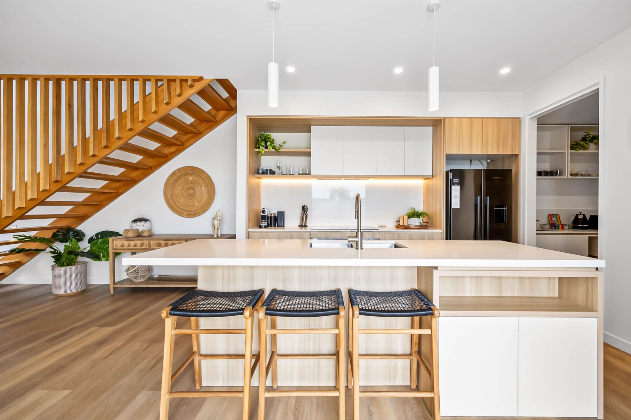 This spacious Bokarina Beach 3-bed home offers A/C, parking, and outdoor spaces perfect for family gatherings. Just a block from Bokarina Beach, start your day with a swim or surf. Explore scenic trails at Point Cartwright Lighthouse or drive to Kawana Waters Marina and Sunshine Plaza for dining and shopping. Ideally located steps from the renowned Boca Restaurant, this property provides a refined coastal lifestyle, with high-end dining options and access to top Sunshine Coast attractions.
The space
This beautifully designed 3-bed, 3-bath home in Bokarina offers modern luxury and coastal relaxation. The bright, open-plan interiors feature sophisticated decor, timber floors, and earthy tones, with ducted A/C and ceiling fans throughout. The kitchen is sleek and fully equipped with modern appliances, whilst the spacious living and dining areas provide a homely feel. Each bedroom is comfortable, with a king, queen, and two single beds. Spa-style bathrooms with rain showers and a bath offer a luxurious way to wash the day away. A dedicated study room and Wi-Fi make it perfect for working remotely. Outside, enjoy alfresco dining in the backyard or relax on the front porch. With garage parking for two vehicles and just a short walk to Bokarina Beach and the renowned Boca Restaurant, this home combines elegance and convenience for the ultimate Sunshine Coast getaway.
 
Living room
- Couch sits 6 people
- TV with streaming available (guests to use their own credentials)
 
Kitchen & Dining Area
- Fully equipped with utensils and cutlery
- Oven and electric stovetop
- The dining area sits 6 people and the countertop area sits 3 people
 
Bathroom & Laundry
- Laundry room available with washer and dryer
- Travel essentials, towels and hairdryer provided
 
Amenity Notes
- Ducted A/C (heating + cooling) throughout
- Ceiling fans throughout
- Wi-Fi available
- Study Room
- Garage parking for 2 small to medium vehicles
- Front porch with seating and backyard with alfresco dining
Local area description
Bokarina is a coastal suburb on the Sunshine Coast. Its beautiful beach, Bokarina, offers a relaxed lifestyle with easy access to outdoor activities like surfing, swimming, and walking along the coastline. The suburb is part of the Kawana Waters, and it's close to shopping centres, schools, and the Sunshine Coast University Hospital. Bokarina's laid-back vibe, combined with its proximity to natural beauty and essential services, makes it an attractive suburb.
House rules
You are staying in a friendly and peaceful neighbourhood and we kindly ask you to respect the community and your surrounding neighbours. The following strict House Rules apply:
 
- No loud noise between 10 pm and 8 am
- No parties or antisocial behaviour
- No additional people are to access the property without our prior approval
- No pets are allowed in the property without approval
- No smoking is allowed at any times
- If you break something, please let us know
- To help protect all floor coverings, do not wear any shoes inside the property
 
Please be aware that excessive noise such as amplified music, vocals or screaming or anti-social behaviour in the property or common areas can cause neighbours to complain to us, the Building Manager, Council Rangers or Police.
 
IMPORTANT:
- Any breach of the House Rules may lead to a $500 fine plus compensation for any cost/damage created and immediate eviction of the property without refund.
- Pets are available on request unless the property states it is pet friendly. Any stays with pets will incur an additional cleaning fee of $200.
 
Finally, when checking out, we kindly ask you for the following:
 
- Please leave all beds unmade
- Please clean up your dishes and put them away
- In case you have rearranged furniture, please put it back to the original location
- Please take out the rubbish and remember to use the right bins
- Please ensure all appliances, A/C and lights are off and doors and windows are closed.
- Please check your accommodation thoroughly before departing to avoid any unintentional items left behind.
 
We are not liable for any items left behind after your stay. In the rare event that a guest reports a missing item, we will make every effort to locate it for you, but we cannot guarantee its retrieval. If the item is found, we will gladly assist in arranging its return to an address within Australia, subject to postage and service fees.
Interaction with guests
Welcome to MadeComfy! Our local team curates stays in exceptional Australian & New Zealand properties, ensuring style, comfort, and prime locations for discerning guests. We prioritise your needs to provide a memorable home-away-from-home experience. Explore our digital guidebooks for local recommendations, and don't hesitate to contact us throughout your stay. We're here to ensure your comfort - enjoy your stay with MadeComfy.
Notes
For your comfort, this property is prepared with professional-grade hotel-style linen, including a three-sheet setup, ensuring a fresh and hygienic sleep experience.
 
Extra Services:
- Early Check-in: Our standard check-in is at 3 pm. To guarantee early access to the property we suggest booking the night before if available. Otherwise, early check-in is subject to availability from the night before at an additional cost.
- Late check-out: Our standard check-out is at 10 am. To guarantee a later check-out of the property we suggest booking an additional night if available. Otherwise, a late check-out is subject to availability from the night before to an additional cost.
- Baggage: For security reasons, we are unable to receive or to keep unattended baggage before check-in or after check-out
- We provide a small welcome amenity pack to get your stay started.
- This booking is protected with coverage for lost baggage and emergency medical expenses, provided by Travel Support with claim upto 500 AUD (T&C Applies). For more details reach out to Guest Support team post booking.
Access description
- The key collection is located onsite. Further details will be provided 3 days before check-in if your booking is successfully reserved.
- Stairs are required to access the front door and the inside of the property.
Getting around
Public Transport
The closest bus stop is located 550 m away from the property on Nicklin Way at Kawana Waters Bowls Club. Please visit Translink's website for more information.
 
Getting There
The property is located 21 km away from Sunshine Coast Airport. By car, the journey will take around 25 minutes. By public transportation, the journey will take around 1 hour.