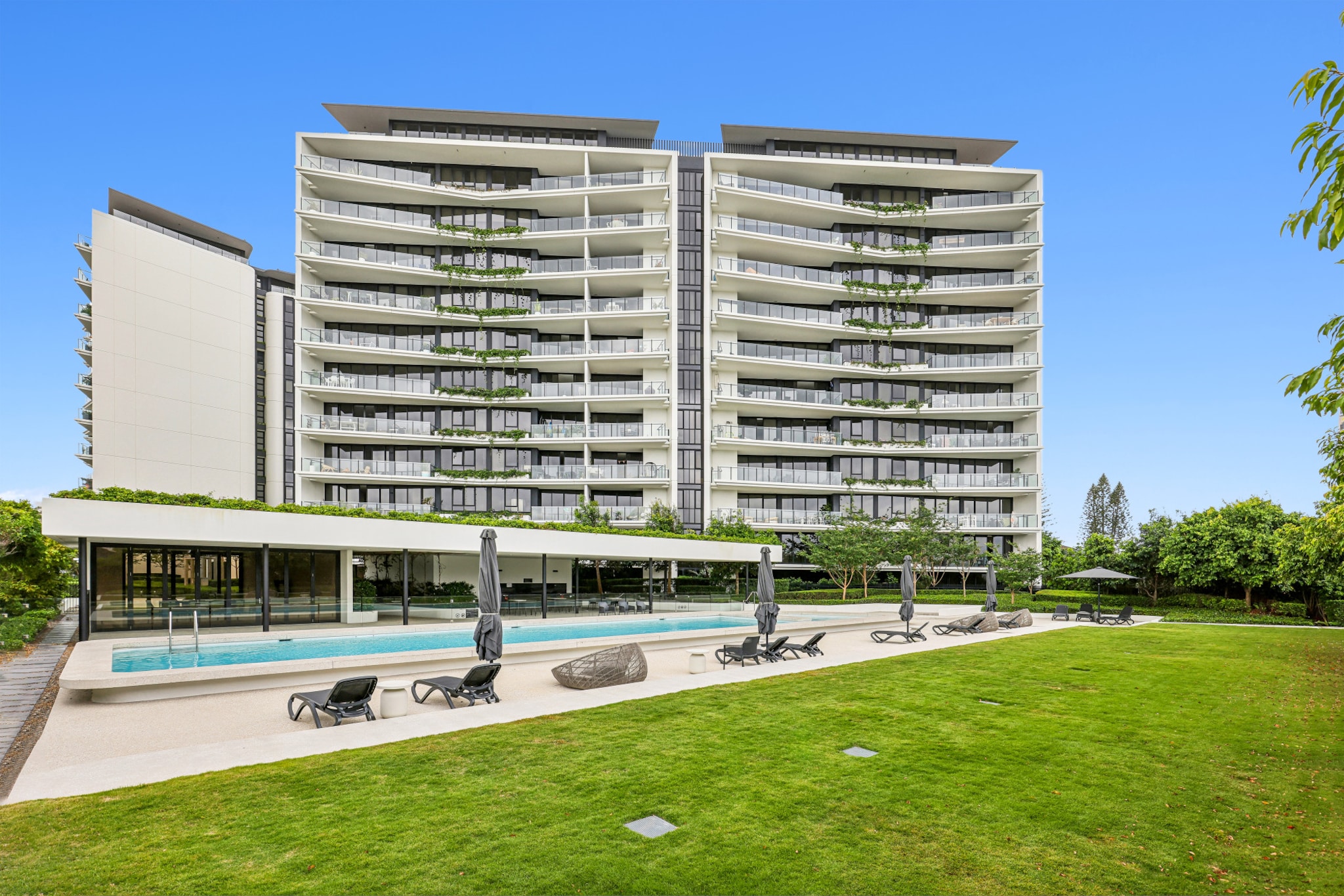 Just steps from Palm Beach, this elegant 2-bed apartment offers spacious interiors and a beautiful balcony, where you can enjoy stunning ocean views whilst sipping your morning coffee or relaxing with sunset cocktails. The property features outstanding amenities, easy access to local shops, and the gorgeous beachfront by your doorstep. Ideal for a family holiday or a getaway with friends, this apartment includes on-site parking, ducted A/C, and self-check-in for a hassle-free experience.
The space
Experience the ultimate getaway in this elegant 2-bed, 2-bath apartment, located less than 100 metres from iconic Palm Beach. The chic interiors feature hotel-like bedrooms with comfortable queen beds and floor-to-ceiling windows that fill the space with natural light and striking ocean views. The modern open-plan kitchen and dining area seamlessly connect to the stylish living space, whilst both bathrooms showcase luxurious walk-in showers. Enjoy the convenience of A/C and ceiling fans or step outside to your private beach-facing balcony with BBQ and seating. Additional amenities include access to a communal resort-style swimming pool, BBQ area, and garden. With underground parking, this chic home is comfortable, convenient, and elegant.
 
Living room
- Couch sits 4 people
- TV with free-to-air channels & streaming available (guests to use their own credentials)
 
Kitchen & Dining Area
- Fully equipped with utensils and cutlery
- Oven and electric stovetop
- Dining area sits 4 people
 
Bathroom & Laundry
- Laundry room available with washer and dryer
- Travel essentials, towels and hairdryer provided
 
Amenity Notes
- Ducted A/C (heating + cooling) throughout
- Ceiling fans in bedrooms
- Wi-Fi available
- Underground parking for 1 vehicle
- Private beach-facing balcony with BBQ and seating
- Communal resort-style swimming pool, BBQ area and garden available for use