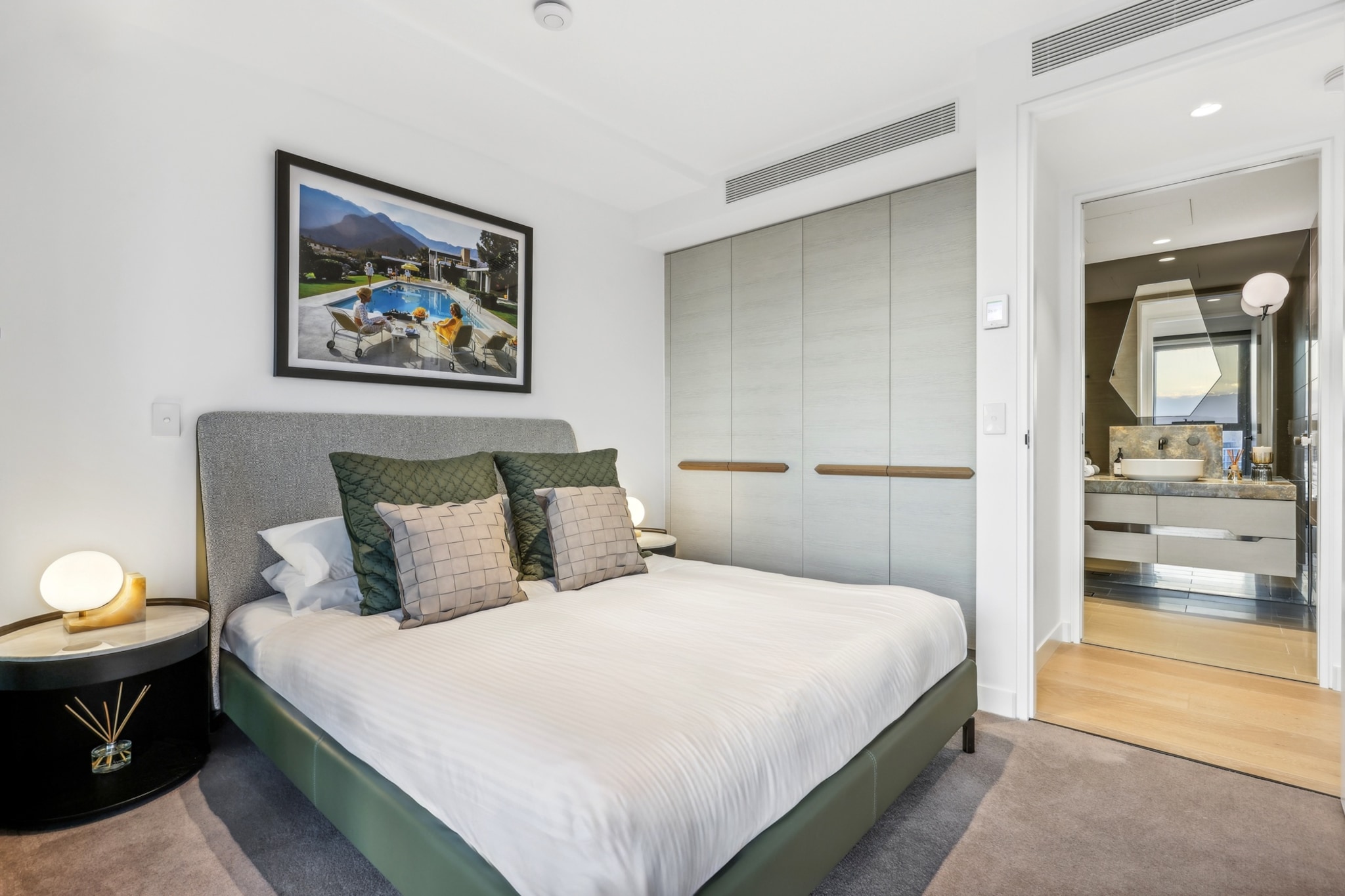 This beautiful 2-bed apartment offers an open-plan design with large windows and a private undercover balcony with impressive water views. Just moments from Surfers Paradise Beach, you'll be near major attractions like Sky Point Observation Deck and Cavill Avenue. With excellent amenities, including a gym, swimming pool, and sauna, you'll find restaurants and public transport nearby. Stay here for the perfect combination of convenience, relaxation, and adventure in the heart of the Gold Coast.
The space
Relax in style at this premium 2-bed, 1-bath apartment, designed with elegance and comfort. Bright and spacious, with large windows flooding the space with natural light, it features modern timber floors, chic contemporary furnishings, and a sophisticated open-plan kitchen, dining, and living area that flows seamlessly onto a private balcony with stunning water views. The elegant bedrooms offer a queen bed and two singles, while the modern bathroom includes a walk-in shower. Ducted air-conditioning throughout ensures year-round comfort, and Wi-Fi keeps you connected. Enjoy access to fantastic communal amenities, including a gym, swimming pool, sauna, lounge, conference room, and garden. Whether you're sipping coffee on the balcony or unwinding in the spacious living area, this apartment blends modern luxury with ultimate convenience for a perfect coastal escape.
Living room
- Couch sits 3 people
- TV with free-to-air channels & streaming available (guests to use their own credentials)
Kitchen & Dining Area
- Fully equipped with utensils and cutlery
- Oven and electric stovetop
- Dining area sits 4 people
Bathroom & Laundry
- Laundry room available with washer and dryer
- Travel essentials, towels and hairdryer provided
Amenity Notes
- Ducted A/C (heating + cooling) throughout
- Wi-Fi available
- 1 Onsite secure parking spot
- Private balcony with seating overlooking the water
- Absolute beachfront location; pool has direct access to the beach
- Communal facilities: Gym, beach front outdoor swimming pool, sun loungers, pool bar, sauna, conference room, lounge, and garden
Local area description
Surfers Paradise is a dynamic and bustling destination that attracts tourists from all over the world. Its combination of stunning natural beauty, modern amenities, and lively atmosphere makes it a popular choice for vacationers seeking sun and a vibrant social scene. It's known for its stunning sandy beaches, vibrant nightlife, and high-rise skyline — the Q1 building, which was once the tallest residential tower in the world, is one of the most prominent landmarks. The area is home to various shopping precincts and dining options. You'll find everything from boutique shops to large shopping centres like Chevron Renaissance and Circle on Cavill. There are also numerous restaurants, cafes, and bars offering a wide range of cuisines. Surfers Paradise is renowned for its lively nightlife which includes nightclubs, bars, and live music venues. The suburb has a light rail system, known as the Gold Coast Light Rail, which provides easy access to neighbouring suburbs and attractions.
House rules
You are staying in a friendly and peaceful neighbourhood and we kindly ask you to respect the community and your surrounding neighbours. The following strict House Rules apply:
- No loud noise between 10 pm and 8 am
- No parties or antisocial behaviour
- No additional people are to access the property without our prior approval
- No pets are allowed in the property without approval
- No smoking is allowed at any times
- If you break something, please let us know
- To help protect all floor coverings, do not wear any shoes inside the property
Please be aware that excessive noise such as amplified music, vocals or screaming or anti-social behaviour in the property or common areas can cause neighbours to complain to us, the Building Manager, Council Rangers or Police.
IMPORTANT:
- Any breach of the House Rules may lead to a $500 fine plus compensation for any cost/damage created and immediate eviction of the property without refund.
- Pets are available on request unless the property states it is pet friendly. Any stays with pets will incur an additional cleaning fee of $200.
Finally, when checking out, we kindly ask you for the following:
- Please leave all beds unmade
- Please clean up your dishes and put them away
- In case you have rearranged furniture, please put it back to the original location
- Please take out the rubbish and remember to use the right bins
- Please ensure all appliances, A/C and lights are off and doors and windows are closed.
- Please check your accommodation thoroughly before departing to avoid any unintentional items left behind.
We are not liable for any items left behind after your stay. In the rare event that a guest reports a missing item, we will make every effort to locate it for you, but we cannot guarantee its retrieval. If the item is found, we will gladly assist in arranging its return to an address within Australia, subject to postage and service fees.
Interaction with guests
Welcome to MadeComfy! Our local team curates stays in exceptional Australian & New Zealand properties, ensuring style, comfort, and prime locations for discerning guests. We prioritise your needs to provide a memorable home-away-from-home experience. Explore our digital guidebooks for local recommendations, and don't hesitate to contact us throughout your stay. We're here to ensure your comfort - enjoy your stay with MadeComfy.
Notes
- For your comfort, this property is prepared with professional-grade hotel-style linen, including a three-sheet setup, ensuring a fresh and hygienic sleep experience.
- This apartment is not affiliated with the on-site staff at the Langham Hotel or Jewel Residences. This apartment is a privately owned and managed residence, if you need anything during your stay, please reach out to us directly.
Extra Services:
- Early Check-in: Our standard check-in is at 3 pm. To guarantee early access to the property we suggest booking the night before if available. Otherwise, early check-in is subject to availability from the night before at an additional cost.
- Late check-out: Our standard check-out is at 10 am. To guarantee a later check-out of the property we suggest booking an additional night if available. Otherwise, a late check-out is subject to availability from the night before to an additional cost.
- Baggage: For security reasons, we are unable to receive or to keep unattended baggage before check-in or after check-out
- We provide a small welcome amenity pack to get your stay started.
- This booking is protected with coverage for lost baggage and emergency medical expenses, provided by Travel Support with claim upto 500 AUD (T&C Applies). For more details reach out to Guest Support team post booking.
Access description
- The key collection is located offsite and is not available 24/7. Further details will be provided 3 days before check-in if your booking is successfully reserved.
Getting around
Public Transport
The closest bus stop is located 94 m from the property on Ferny Ave at Old Burleigh Rd at Fern Street. Please visit Translink's website for more information.
Getting There
The property is located 30 km away from Gold Coast Airport. By car, the journey will take around 45 minutes. By public transportation, the journey will take around 1 hour.