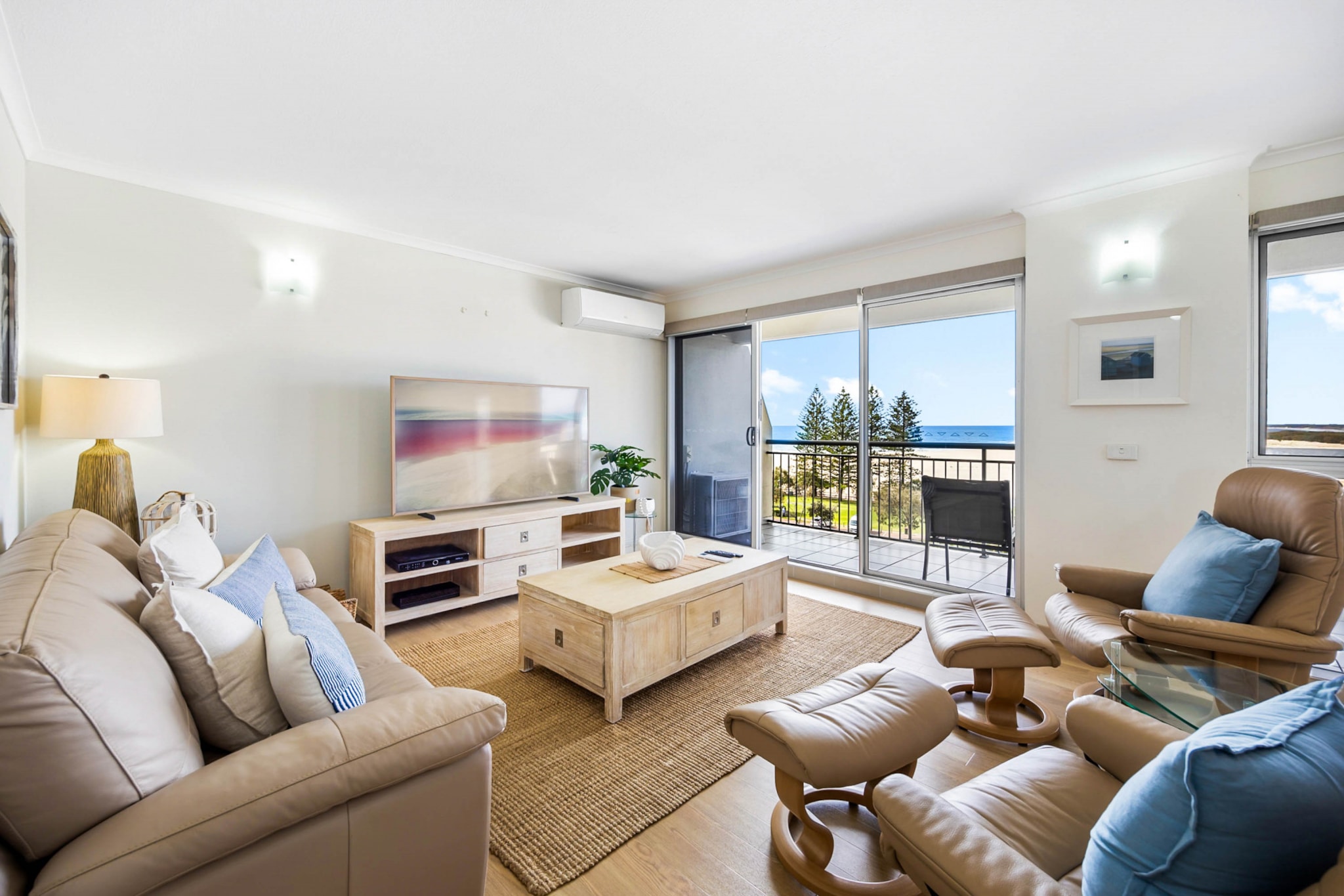 Welcome to your beachside paradise! This oceanfront 3-bedroom apartment is just steps from Bulcock Beach and a 5-minute walk to Kings Beach. Enjoy local cafes for morning coffee or lunch by the shore. Every Sunday, explore the Caloundra Street Markets with 120+ stalls. Adventure awaits on the scenic Caloundra Coastal path. With easy access to shops and restaurants, this is more than a getaway—it's a dream retreat waiting to be enjoyed!
The space
This bright and spacious 3-bedroom, 2-bathroom apartment in Caloundra is the ideal retreat for those seeking comfort and relaxation. The master bedroom boasts a private ensuite and split air conditioning for added convenience. The inviting living area, featuring elegant timber floors and large windows, is flooded with natural light, creating a warm atmosphere. Enjoy stunning ocean views from the open-plan kitchen and dining area, perfect for memorable meals. Step outside to your private undercover balcony for alfresco dining with beautiful beach vistas, or take a refreshing dip in the communal outdoor swimming pool. Experience the perfect blend of beachside charm and modern living in this exceptional apartment.
Living room
- 2 sofas, seating 5 people
- TV with streaming available (guests to use their own credentials)
Kitchen & Dining Area
- Fully equipped with utensils and cutlery
- Oven and electric stovetop
- Dining area and outdoor seating sits 6 people
Bathroom & Laundry
- Laundry room available with washer and dryer
- Travel essentials, towels and hairdryer provided
Amenity Notes
- Split A/C (heating + cooling) in the master bedroom and living area
- Fan available in small bedroom
- Wi-Fi available
- Garage parking for 1 vehicle
- Private undercover balcony overlooking the beach with alfresco dining
- Communal outdoor swimming pool
Local area description
Caloundra is a coastal suburb on the Sunshine Coast in Queensland. Known for its beautiful beaches like Kings Beach and Bulcock Beach, it's a popular destination for people seeking a relaxed, beachside lifestyle. The area offers a mix of natural attractions, including scenic coastal walks, family-friendly parks, and vibrant markets. Caloundra has a laid-back atmosphere but also features growing amenities, shops, cafes, and restaurants, making it ideal for families, retirees, and holidaymakers. Its proximity to Brisbane (about 90 minutes away) adds to its appeal as a weekend getaway spot.
House rules
You are staying in a friendly and peaceful neighbourhood and we kindly ask you to respect the community and your surrounding neighbours. The following strict House Rules apply:
- No loud noise between 10 pm and 8 am
- No parties or antisocial behaviour
- No additional people are to access the property without our prior approval
- No pets are allowed in the property without approval
- No smoking is allowed at any times
- If you break something, please let us know
- To help protect all floor coverings, do not wear any shoes inside the property
Please be aware that excessive noise such as amplified music, vocals or screaming or anti-social behaviour in the property or common areas can cause neighbours to complain to us, the Building Manager, Council Rangers or Police.
IMPORTANT:
- Any breach of the House Rules may lead to a $500 fine plus compensation for any cost/damage created and immediate eviction of the property without refund.
- Pets are available on request unless the property states it is pet friendly. Any stays with pets will incur an additional cleaning fee of $200.
Finally, when checking out, we kindly ask you for the following:
- Please leave all beds unmade
- Please clean up your dishes and put them away
- In case you have rearranged furniture, please put it back to the original location
- Please take out the rubbish and remember to use the right bins
- Please ensure all appliances, A/C and lights are off and doors and windows are closed.
- Please check your accommodation thoroughly before departing to avoid any unintentional items left behind.
We are not liable for any items left behind after your stay. In the rare event that a guest reports a missing item, we will make every effort to locate it for you, but we cannot guarantee its retrieval. If the item is found, we will gladly assist in arranging its return to an address within Australia, subject to postage and service fees.
Interaction with guests
Welcome to MadeComfy! Our local team curates stays in exceptional Australian & New Zealand properties, ensuring style, comfort, and prime locations for discerning guests. We prioritise your needs to provide a memorable home-away-from-home experience. Explore our digital guidebooks for local recommendations, and don't hesitate to contact us throughout your stay. We're here to ensure your comfort - enjoy your stay with MadeComfy.
Notes
- For your comfort, this property is prepared with professional-grade hotel-style linen, including a three-sheet setup, ensuring a fresh and hygienic sleep experience.
- No coffee machine is available
Extra Services:
- Early Check-in: Our standard check-in is at 3 pm. To guarantee early access to the property we suggest booking the night before if available. Otherwise, early check-in is subject to availability from the night before at an additional cost.
- Late check-out: Our standard check-out is at 10 am. To guarantee a later check-out of the property we suggest booking an additional night if available. Otherwise, a late check-out is subject to availability from the night before to an additional cost.
- Baggage: For security reasons, we are unable to receive or to keep unattended baggage before check-in or after check-out
- We provide a small welcome amenity pack to get your stay started.
- This booking is protected with coverage for lost baggage and emergency medical expenses, provided by Travel Support with claim upto 500 AUD (T&C Applies). For more details reach out to Guest Support team post booking.
Access description
- The key collection is located onsite. Further details will be provided 3 days before check-in if your booking is successfully reserved.
- 4 flights of stairs to access the front door of the property.
Getting around
Public Transport
Caloundra station is located 220 m away from the property. Please visit Translink's website for more information.
Getting There
The property is located 29 km away from Sunshine Coast Airport. By car, the journey will take around 40 minutes. By public transportation, the journey will take around 1 hour and 30 minutes.