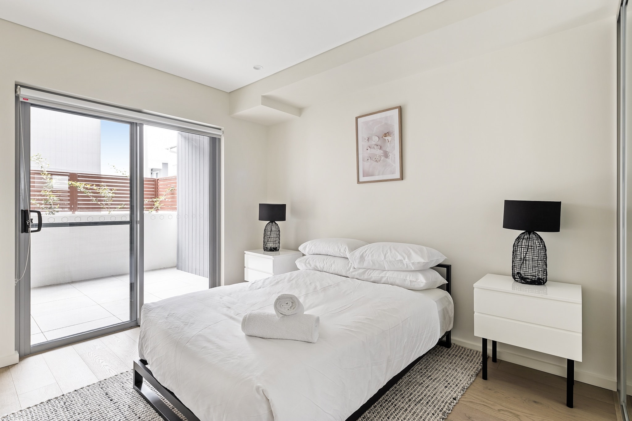 Experience the relaxed charm of Kiama from this beautiful 3-bed ground-floor property featuring modern interiors, on-site parking and air conditioning. Just minutes from iconic attractions like the Kiama Blowhole and Lighthouse, the lush Minnamurra Rainforest, and the picturesque Kiama Coastal Walk, this property makes exploring NSW’s South Coast easy. From here, you'll easily visit nearby beaches, take a scenic drive to Seven Mile Beach, or enjoy a day of thrills at Jamberoo Action Park.
The space
This bright, spacious property is modern, elegant and comfortable. Featuring a stylish open-plan kitchen, dining, and living area, the home is filled with natural light thanks to large windows and thoughtfully designed interiors. With three beautifully appointed bedrooms — one with a king bed, one with a double, and another with a queen — each room provides lots of space and serene views. Two contemporary bathrooms, each equipped with a sleek walk-in shower, add a touch of luxury. Step out onto the private balcony for alfresco dining with the BBQ, where you can enjoy the garden surroundings in your own quiet oasis. With Kiama’s local cafés, beaches, and attractions just minutes away, this property is your perfect base for a memorable South Coast escape.
Living room
- Spacious living area with lounge
- Smart TV with free air channels & streaming available (guests to use their own credentials)
Kitchen & Dining Area
- Fully equipped with utensils and cutlery
- Oven and gas stovetop
- Dining area sits 6 people and countertop area sits 2 people
Bathroom & Laundry
- Laundry room available with washer and dryer combo
- Travel essentials, towels and hairdryer provided
Amenity Notes
- Ducted and split A/C (heating + cooling)
- Wi-Fi is provided
- Basement parking for 2 large vehicle
- Balcony with alfresco dining, BBQ and garden
Local area description
Kiama is a picturesque coastal town in the Illawarra region of New South Wales. Known for its stunning landscapes, it's famous for the Kiama Blowhole — a natural rock formation where seawater shoots up into the air, creating an impressive display. The town offers lush greenery, beautiful beaches like Surf Beach and Jones Beach, and coastal walks with breathtaking views of the Pacific Ocean. Kiama exudes a relaxed atmosphere, with a charming town centre featuring cafes, boutique shops, and a friendly community vibe. With its blend of natural beauty and coastal charm, Kiama is a sought-after destination for tourists and locals seeking a tranquil seaside retreat.
House rules
You are staying in a friendly and peaceful neighbourhood and we kindly ask you to respect the community and your surrounding neighbours. The following strict House Rules apply:
- No loud noise between 10 pm and 8 am
- No parties or antisocial behaviour
- No additional people are to access the property without our prior approval
- Pets are allowed upon request, Please note that an additional cleaning fee of AUD 200 will apply for stays with pets.
- No smoking is allowed at any times
- If you break something, please let us know
- To help protect all floor coverings, do not wear any shoes inside the property
Please be aware that excessive noise such as amplified music, vocals or screaming or anti-social behaviour in the property or common areas can cause neighbours to complain to us, the Building Manager, Council Rangers or Police.
IMPORTANT:
- Any breach of the House Rules may lead to a $500 fine plus compensation for any cost/damage created and immediate eviction of the property without refund.
Finally, when checking out, we kindly ask you for the following:
- Please leave all beds unmade
- Please clean up your dishes and put them away
- In case you have rearranged furniture, please put it back to the original location
- Please take out the rubbish and remember to use the right bins
- Please ensure all appliances, A/C and lights are off and doors and windows are closed.
- Please check your accommodation thoroughly before departing to avoid any unintentional items left behind.
We are not liable for any items left behind after your stay. In the rare event that a guest reports a missing item, we will make every effort to locate it for you, but we cannot guarantee its retrieval. If the item is found, we will gladly assist in arranging its return to an address within Australia, subject to postage and service fees.
Important Notice: Garage Security Alert
To ensure everyone's safety, we kindly ask you to follow these precautions during your stay:
- Be Vigilant: If you see anyone in the garage whom you do not recognise, remain aware of your surroundings and proceed with caution.
- Access Control: Do not allow unknown vehicles to follow you into the garage. If another car approaches while you are entering, ensure they have the appropriate access before proceeding.
- Walking Through the Garage: Remain observant when walking through the garage, especially if you notice unfamiliar individuals.
- Security Cameras: Our cameras are being upgraded, but not all areas are covered at this time. Please stay alert and take precautions.
- Reporting Issues: If you notice anything suspicious or if something is missing, please file a police report and inform Building Management immediately.
We appreciate your cooperation in helping maintain a safe and secure environment for everyone. Thank you for your understanding.
Interaction with guests
Welcome to MadeComfy! Our local team curates stays in exceptional Australian & New Zealand properties, ensuring style, comfort, and prime locations for discerning guests. We prioritise your needs to provide a memorable home-away-from-home experience. Explore our digital guidebooks for local recommendations, and don't hesitate to contact us throughout your stay. We're here to ensure your comfort - enjoy your stay with MadeComfy.
Notes
- For your comfort, this property is prepared with professional-grade hotel-style linen, including a three-sheet setup, ensuring a fresh and hygienic sleep experience.
- E-bikes shouldn't be charged overnight or left on without supervision.
Pet Rules:
- We only welcome small to medium-sized pets upon request, additional fees apply.
- Guests are required to contact the host and provide a picture of their pet prior to arrival.
Extra Services:
- Early Check-in: Our standard check-in is at 3 pm. To guarantee early access to the property we suggest booking the night before if available. Otherwise, early check-in is subject to availability from the night before at an additional cost.
- Late check-out: Our standard check-out is at 10 am. To guarantee a later check-out of the property we suggest booking an additional night if available. Otherwise, a late check-out is subject to availability from the night before to an additional cost.
- Baggage: For security reasons, we are unable to receive or to keep unattended baggage before check-in or after check-out
- We provide a small welcome amenity pack to get your stay started.
Important Notice: Garage Security Alert
To ensure everyone's safety, we kindly ask you to follow these precautions during your stay:
- Be Vigilant: If you see anyone in the garage whom you do not recognise, remain aware of your surroundings and proceed with caution.
- Access Control: Do not allow unknown vehicles to follow you into the garage. If another car approaches while you are entering, ensure they have the appropriate access before proceeding.
- Walking Through the Garage: Remain observant when walking through the garage, especially if you notice unfamiliar individuals.
- Security Cameras: Our cameras are being upgraded, but not all areas are covered at this time. Please stay alert and take precautions.
- Reporting Issues: If you notice anything suspicious or if something is missing, please file a police report and inform Building Management immediately.
We appreciate your cooperation in helping maintain a safe and secure environment for everyone. Thank you for your understanding.
- This booking is protected with coverage for lost baggage and emergency medical expenses, provided by Travel Support with claim upto 500 AUD (T&C Applies). For more details reach out to Guest Support team post booking.
Access description
- The key collection is located onsite. Further details will be provided 3 days before check-in if your booking is successfully reserved.
Getting around
Public Transport
The closest bus stop is located 800 m from the property on Hillview Cct after Stewart Pl. Please visit Transport NSW website for more information.
Getting There
The property is located 20 km away from Shellharbour Airport. By car, the journey will take around 20 minutes. By public transportation, the journey will take around 1 hour.