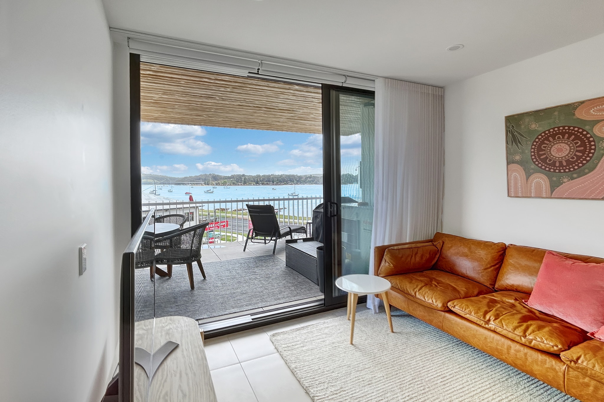 This stylish 2-bed apartment offers a bright, open-plan living space with a private balcony to enjoy coffee or an alfresco meal overlooking the water. Just minutes from Batemans Bay's attractions, you can explore Clyde River National Park, relax on Surfside Beach, or visit the charming kangaroos at Pebbly Beach. With modern appliances and a convenient location near Birdland Animal Park and the Eurobodalla Regional Botanic Gardens, this property is your gateway to coastal adventures.
The space
Joy at Ohana is an elegant 2-bed, 2-bath apartment with large windows and tasteful decor. The sophisticated bedrooms include a queen bed in the master and a double in the second room. The stylish bathrooms feature sleek finishes and walk-in showers. With split-system air-conditioning, internal laundry, Wi-Fi, and underground parking, every detail is designed for convenience. The private undercover balcony boasts stunning bay views, alfresco dining, seating, and a BBQ. Residents can also enjoy access to a communal swimming pool. You'll be near Batemans Bay's attractions, including Clyde River National Park and Birdland Animal Park. Welcome the natural beauty and good vibes of Batemans Bay at Joy at Ohana!
Living room
- Couch sits 3 people + armchair
- Additional entrance lounge room with couch sitting 2 people
- TV with free-to-air channels & streaming available (guests to use their own credentials)
Kitchen & Dining Area
- Fully equipped with utensils and cutlery
- Oven and induction stovetop
- Dining area seats 4 people and countertop area seats 2 people
Bathroom & Laundry
- Laundry room available with washer and dryer
- Travel essentials, towels and hairdryer provided
Amenity Notes
- Split A/C (heating + cooling) throughout
- Wi-Fi available
- Underground parking for 1 medium-sized vehicle
- Side balcony to store bikes
- Private undercover balcony overlooking the bay with alfresco dining set up, seating and BBQ
- Communal rooftop swimming pool
Local area description
Batemans Bay, nestled on the stunning south coast of New South Wales, embodies a harmonious blend of coastal charm and natural beauty. As the region's commercial hub, it offers a picturesque waterfront embraced by pristine beaches, including the popular Surfside and Catalina. The Clyde River, weaving through the town, provides a serene backdrop for leisurely activities such as fishing, boating, and kayaking. Its vibrant community celebrates diverse events, from local markets showcasing regional produce to cultural festivals. With its proximity to Murramarang National Park and Eurobodalla National Park, Batemans Bay beckons nature enthusiasts with opportunities for bushwalks, wildlife spotting, and breathtaking scenic lookouts. The town's relaxed ambience, coastal allure, and abundant outdoor pursuits, makes it a captivating destination for residents and tourists.
House rules
You are staying in a friendly and peaceful neighbourhood and we kindly ask you to respect the community and your surrounding neighbours. The following strict House Rules apply:
- No loud noise between 10 pm and 8 am
- No parties or antisocial behaviour
- No additional people are to access the property without our prior approval
- No pets are allowed in the property without approval
- No smoking is allowed at any times
- If you break something, please let us know
- To help protect all floor coverings, do not wear any shoes inside the property
Please be aware that excessive noise such as amplified music, vocals or screaming or anti-social behaviour in the property or common areas can cause neighbours to complain to us, the Building Manager, Council Rangers or Police.
IMPORTANT:
- Any breach of the House Rules may lead to a $500 fine plus compensation for any cost/damage created and immediate eviction of the property without refund.
- Pets are available on request unless the property states it is pet friendly. Any stays with pets will incur an additional cleaning fee of $200.
Finally, when checking out, we kindly ask you for the following:
- Please leave all beds unmade
- Please clean up your dishes and put them away
- In case you have rearranged furniture, please put it back to the original location
- Please take out the rubbish and remember to use the right bins
- Please ensure all appliances, A/C and lights are off and doors and windows are closed.
- Please check your accommodation thoroughly before departing to avoid any unintentional items left behind.
We are not liable for any items left behind after your stay. In the rare event that a guest reports a missing item, we will make every effort to locate it for you, but we cannot guarantee its retrieval. If the item is found, we will gladly assist in arranging its return to an address within Australia, subject to postage and service fees.
Interaction with guests
Welcome to MadeComfy! Our local team curates stays in exceptional Australian & New Zealand properties, ensuring style, comfort, and prime locations for discerning guests. We prioritise your needs to provide a memorable home-away-from-home experience. Explore our digital guidebooks for local recommendations, and don't hesitate to contact us throughout your stay. We're here to ensure your comfort - enjoy your stay with MadeComfy.
Notes
- For your comfort, this property is prepared with professional-grade hotel-style linen, including a three-sheet setup, ensuring a fresh and hygienic sleep experience.
- The pool may be closed at any time for maintenance.
Extra Services:
- Early Check-in: Our standard check-in is at 3 pm. To guarantee early access to the property we suggest booking the night before if available. Otherwise, early check-in is subject to availability from the night before at an additional cost.
- Late check-out: Our standard check-out is at 10 am. To guarantee a later check-out of the property we suggest booking an additional night if available. Otherwise, a late check-out is subject to availability from the night before to an additional cost.
- Baggage: For security reasons, we are unable to receive or to keep unattended baggage before check-in or after check-out
- We provide a small welcome amenity pack to get your stay started.
- This booking is protected with coverage for lost baggage and emergency medical expenses, provided by Travel Support with claim upto 500 AUD (T&C Applies). For more details reach out to Guest Support team post booking.
Access description
- The key collection is located onsite. Further details will be provided 3 days before check-in if your booking is successfully reserved.
Getting around
Public Transport
The closest bus stop is located 52 m from the property on Beach Rd at Herarde St. Please visit Transport NSW website for more information.
Getting There
The property is located 29 km away from Moruya Airport. By car, the journey will take around 25 minutes. By public transport the journey will take around 1 hour and 5 minutes.