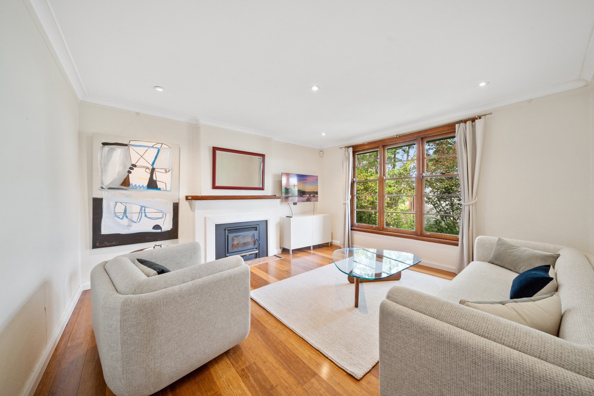 Discover a charming 3-bedroom house in Narrabundah, blending comfort with convenience. This inviting home features spacious interiors, outdoor parking, and a serene atmosphere, perfect for families or groups. Enjoy seamless self-check-in, ample living space, and easy access to local Canberra attractions. Whether youâ€™re unwinding indoors or exploring nearby, this property promises a memorable stay.
The space
This beautiful 3-bedroom house offers a harmonious blend of style and comfort. With 3 single beds, and 1 queen bed, itâ€™s ideal for families or groups. The spacious living room features timber floors, a 3-seater couch, and a TV with free-to-air channels and streaming services. Blackout blinds ensure restful sleep across all bedrooms, while the modern kitchen and dining area cater to your culinary needs. Outside, a lush backyard garden offers a tranquil escape with outdoor seating accessible via the kitchen or main bedroom. The house also features ducted heating and cooling for comfort in all seasons.
 
Living Room
-Couch seats 3 people + chair
-TV with free-to-air and streaming options (guests to use their own credentials)
 
Kitchen & Dining Area
-Fully equipped with utensils and cutlery
-Gas stovetop and electric oven
-Dining table seats 6 + countertop seats 3
 
Bathroom & Laundry
-Laundry room with washer and dryer
-Travel essentials, towels, and hairdryer provided
 
Amenity Notes
-Onsite parking: driveway for 2 vehicles
-Ducted heating and cooling throughout the house
-Wi-Fi available
-Backyard garden with outdoor seating