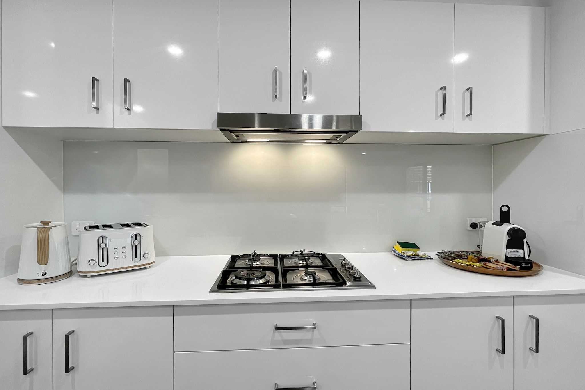 Experience this bright and modern 4-bedroom house in Batemans Bay, offering a serene escape with a spacious interior and lush outdoor areas. Perfect for families or groups, it features a double garage, two living rooms, and a private garden. Relax in the cosy lounges or explore nearby coastal attractions. Self-check-in ensures convenience, with a digital lock for easy access. Enjoy a comfortable stay with Wi-Fi and all essential amenities provided.
The space
This contemporary home boasts four generously sized bedrooms, each equipped with comfortable bedding and ample storage. The master bedroom includes an en-suite bathroom and a walk-in robe, providing a private retreat. The open-plan living area is adorned with stylish décor, featuring two lounges that comfortably seat nine guests, leading to a private garden perfect for outdoor relaxation. The modern kitchen is fully equipped with a gas stovetop, electric oven, and essential appliances, complemented by a dining area that seats six. Additional amenities include a private laundry room with a washer and dryer combo, ensuring a seamless stay.
Living Room
-Two lounges seating a total of 9 people
-TV with Free-to-Air channels (guests to use their own credentials)
Kitchen & Dining Area
-Fully equipped with cookware, cutlery, and utensils
-Gas stovetop and electric oven
-Dining area seats 6; countertop seats 3
Bathroom & Laundry
-Two bathrooms, including an en-suite in the master bedroom
-Laundry room available with washer and dryer combo
-Travel essentials, towels, and hairdryer provided
Amenity Notes
-Onsite double garage with 2.1m height restriction, accommodates medium to large vehicles
-Air conditioning: Split system in main living/dining area; portable fans in bedrooms
-Private garden accessible from the living area
-Wi-Fi is available
Local area description
Batemans Bay is a picturesque coastal town known for its stunning beaches and vibrant community. Explore the Clyde River, enjoy fresh seafood at local eateries, or visit the nearby Murramarang National Park for hiking and wildlife spotting. The town offers a perfect blend of relaxation and adventure.
House rules
You are staying in a friendly and peaceful neighbourhood and we kindly ask you to respect the community and your surrounding neighbours. The following strict House Rules apply:
- No loud noise between 10 pm and 8 am
- No parties or antisocial behaviour
- No additional people are to access the property without our prior approval
- No pets are allowed in the property without approval
- No smoking is allowed at any times
- If you break something, please let us know
- To help protect all floor coverings, do not wear any shoes inside the property
Please be aware that excessive noise such as amplified music, vocals or screaming or anti-social behaviour in the property or common areas can cause neighbours to complain to us, the Building Manager, Council Rangers or Police.
IMPORTANT:
- Any breach of the House Rules may lead to a $500 fine plus compensation for any cost/damage created and immediate eviction of the property without refund.
- Pets are available on request unless the property states it is pet friendly. Any stays with pets will incur an additional cleaning fee of $200.
Finally, when checking out, we kindly ask you for the following:
- Please leave all beds unmade
- Please clean up your dishes and put them away
- In case you have rearranged furniture, please put it back to the original location
- Please take out the rubbish and remember to use the right bins
- Please ensure all appliances, A/C and lights are off and doors and windows are closed.
- Please check your accommodation thoroughly before departing to avoid any unintentional items left behind.
We are not liable for any items left behind after your stay. In the rare event that a guest reports a missing item, we will make every effort to locate it for you, but we cannot guarantee its retrieval. If the item is found, we will gladly assist in arranging its return to an address within Australia, subject to postage and service fees.
Interaction with guests
Welcome to MadeComfy! Our local team curates stays in exceptional Australian & New Zealand properties, ensuring style, comfort, and prime locations for discerning guests. We prioritise your needs to provide a memorable home-away-from-home experience. Explore our digital guidebooks for local recommendations, and don't hesitate to contact us throughout your stay. We're here to ensure your comfort - enjoy your stay with MadeComfy.
Notes
For your comfort, this property is prepared with professional-grade hotel-style linen, including a three-sheet setup, ensuring a fresh and hygienic sleep experience.
Extra Services:
- Early Check-in: Our standard check-in is at 3 pm. To guarantee early access to the property we suggest booking the night before if available. Otherwise, early check-in is subject to availability from the night before at an additional cost.
- Late check-out: Our standard check-out is at 10 am. To guarantee a later check-out of the property we suggest booking an additional night if available. Otherwise, a late check-out is subject to availability from the night before to an additional cost.
- Baggage: For security reasons, we are unable to receive or to keep unattended baggage before check-in or after check-out
- We provide a small welcome amenity pack to get your stay started.
- This booking is protected with coverage for lost baggage and emergency medical expenses, provided by Travel Support with claim upto 500 AUD (T&C Applies). For more details reach out to Guest Support team post booking.
Access description
Key collection is onsite. Further details will be provided 3 days before check-in if your booking is successfully reserved.
There are stairs inside the property
Getting around
Public Transport: Local bus services connect Batemans Bay to surrounding areas, with stops within walking distance.
Getting There: Canberra Airport is approximately a 2-hour drive (150 km), and Sydney CBD is about 4 hours away by car (280 km).