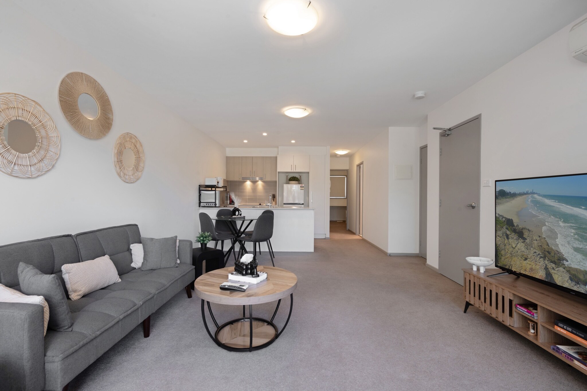 Discover this elegant 2-bedroom apartment in Franklin, designed for comfort and convenience. Enjoy the spacious interiors, blackout blinds, and a private balcony. Perfect for small families or couples, it features a sofa bed, Wi-Fi, and secure underground parking. Located near local shops and dining, this home offers the perfect retreat with easy access to nearby attractions and public transport. Enjoy self-check-in and a seamless stay in this welcoming space.
The space
This inviting apartment boasts a stylish and functional layout, featuring two bedrooms and a modern bathroom. The master bedroom is fitted with a queen bed, blackout blinds, and ample storage, while the second room provides a cosy single bed, ideal for extra guests. The open-plan living area includes a comfortable couch for two, a TV, and direct access to a private balcony perfect for morning coffee or evening relaxation. The fully equipped kitchen offers an oven, stovetop, and dining area that seats four. Complementing this serene space is underground parking and essential amenities, ensuring a comfortable and convenient stay.
Living Room
-Couch seats 2 people
-TV with Free-to-Air channels (guests to use their own credentials)
-Sofa bed: Pull-out style, accommodates one guest
Kitchen & Dining Area
-Fully equipped with cookware, cutlery, and utensils
-Electric oven and stovetop
-Dining area seats 4
Bathroom & Laundry
-Laundry room available with washer and dryer
-Travel essentials, towels and hairdryer provided
Amenity Notes
-Underground parking for 1 car, 2.1m height restriction
-Blackout blinds in bedrooms and living room
-Private balcony with outdoor seating
-Wi-Fi is available
Local area description
Franklin is a vibrant suburb located just minutes from Canberra's heart, offering a mix of urban conveniences and serene green spaces. Explore nearby cafes and restaurants, or stroll through Franklin Wetlands and Mulligans Flat Nature Reserve. With excellent transport links, including the light rail, it's easy to access the city’s cultural and shopping hubs. This location offers a blend of relaxation and activity for an enriching stay.
House rules
You are staying in a friendly and peaceful neighbourhood and we kindly ask you to respect the community and your surrounding neighbours. The following strict House Rules apply:
- No loud noise between 10 pm and 8 am
- No parties or antisocial behaviour
- No additional people are to access the property without our prior approval
- No pets are allowed in the property without approval
- No smoking is allowed at any times
- If you break something, please let us know
- To help protect all floor coverings, do not wear any shoes inside the property
Please be aware that excessive noise such as amplified music, vocals or screaming or anti-social behaviour in the property or common areas can cause neighbours to complain to us, the Building Manager, Council Rangers or Police.
IMPORTANT:
- Any breach of the House Rules may lead to a $500 fine plus compensation for any cost/damage created and immediate eviction of the property without refund.
- Pets are available on request unless the property states it is pet friendly. Any stays with pets will incur an additional cleaning fee of $200.
Finally, when checking out, we kindly ask you for the following:
- Please leave all beds unmade
- Please clean up your dishes and put them away
- In case you have rearranged furniture, please put it back to the original location
- Please take out the rubbish and remember to use the right bins
- Please ensure all appliances, A/C and lights are off and doors and windows are closed.
- Please check your accommodation thoroughly before departing to avoid any unintentional items left behind.
We are not liable for any items left behind after your stay. In the rare event that a guest reports a missing item, we will make every effort to locate it for you, but we cannot guarantee its retrieval. If the item is found, we will gladly assist in arranging its return to an address within Australia, subject to postage and service fees.
Interaction with guests
Welcome to MadeComfy! Our local team curates stays in exceptional Australian & New Zealand properties, ensuring style, comfort, and prime locations for discerning guests. We prioritise your needs to provide a memorable home-away-from-home experience. Explore our digital guidebooks for local recommendations, and don't hesitate to contact us throughout your stay. We're here to ensure your comfort - enjoy your stay with MadeComfy.
Notes
For your comfort, this property is prepared with professional-grade hotel-style linen, including a three-sheet setup, ensuring a fresh and hygienic sleep experience.
Extra Services:
- Early Check-in: Our standard check-in is at 3 pm. To guarantee early access to the property we suggest booking the night before if available. Otherwise, early check-in is subject to availability from the night before at an additional cost.
- Late check-out: Our standard check-out is at 10 am. To guarantee a later check-out of the property we suggest booking an additional night if available. Otherwise, a late check-out is subject to availability from the night before to an additional cost.
- Baggage: For security reasons, we are unable to receive or to keep unattended baggage before check-in or after check-out
- We provide a small welcome amenity pack to get your stay started.
- This booking is protected with coverage for lost baggage and emergency medical expenses, provided by Travel Support with claim upto 500 AUD (T&C Applies). For more details reach out to Guest Support team post booking.
Access description
Key collection is onsite. Further details will be provided three days before check-in, once your booking is successfully reserved.
Getting around
Public Transport: The nearest light rail station is a short walk away, connecting you to Canberra's CBD in under 15 minutes.
Getting There: Canberra Airport is a 20-minute drive, and Canberra's CBD is accessible in 15 minutes by car.