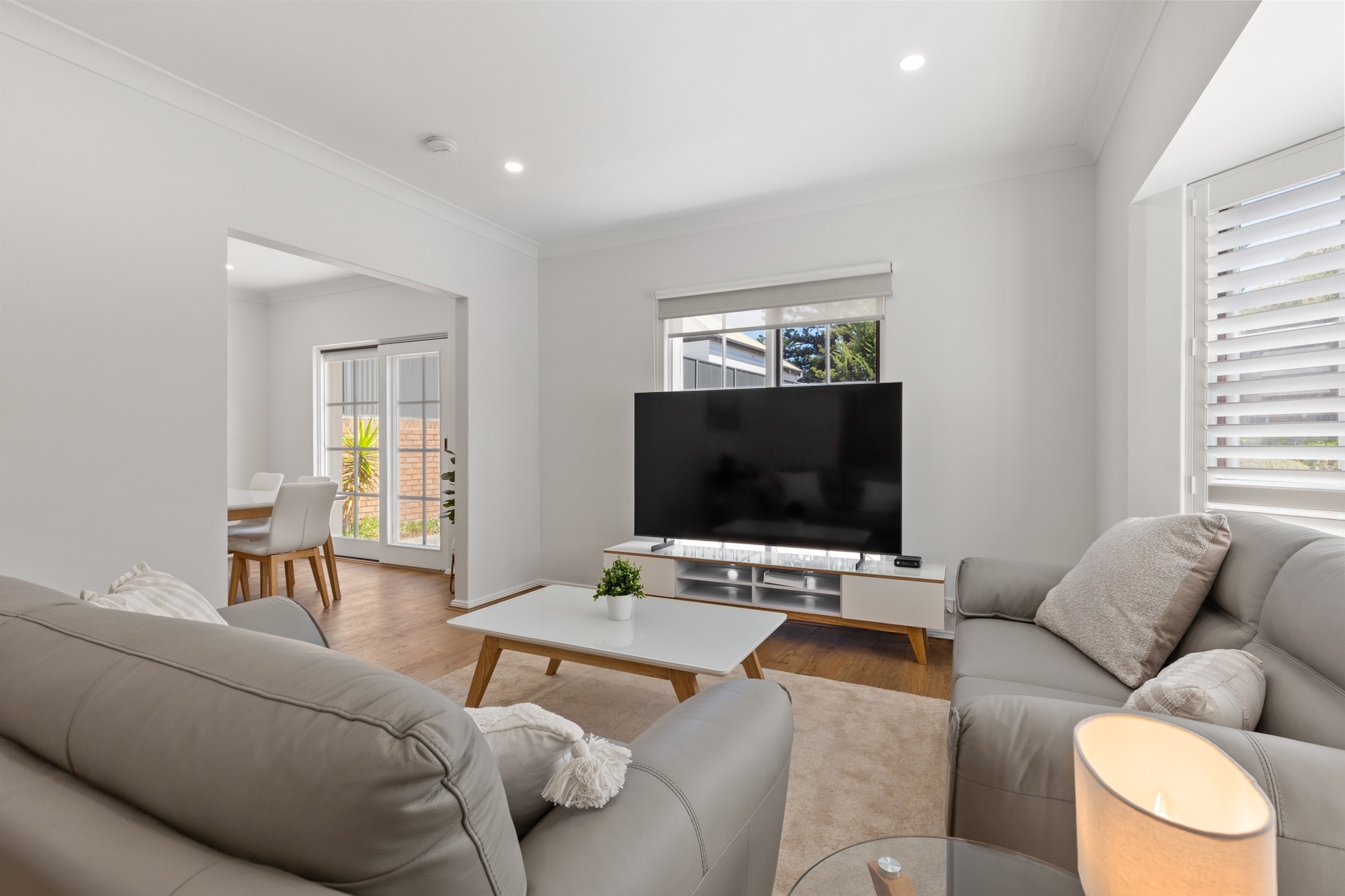 Discover the charm of this inviting 2-bedroom, 1-bathroom house nestled in Glenelg South. Perfect for families or groups, it offers self-check-in, a private garage for medium-sized vehicles, and a fenced courtyard for relaxed outdoor moments. With blackout blinds, a fully equipped kitchen, and a stylish living area, this property ensures a comfortable stay near local attractions and Glenelg Beach.
The space
Step into this delightful home offering a blend of comfort and convenience. The two bedrooms include one queen-sized and two single beds, all fitted with blackout blinds and plush mattresses. The airy living space features a cosy couch, a TV, and tasteful dÃ©cor. The kitchen is fully equipped with an oven and stovetop, perfect for whipping up delicious meals. The dining area seats six, with an additional countertop seating area. Outdoor enthusiasts will appreciate the fenced courtyard and BBQ, ideal for alfresco moments. With on-site garage parking and a keyless entry system, your holiday experience is seamless from start to finish.
 
Living Room:
-Couch seats 4 people
-TV with free-to-air channels
 
Kitchen & Dining Area:
-Fully equipped with cutlery and utensils
-Oven and gas stovetop
-Dining area seats 6 people + countertop seats 2
 
Bathroom & Laundry:
-Laundry room available with washer and dryer
-Travel essentials, towels and hairdryer provided
 
Amenity Notes:
-Private garage for medium-sized vehicle
-Wi-Fi is available
-Study Nook
-Courtyard with alfresco dining and BBQ
-Easy access to the beach and nearby cafes on Broadway
-Shark vacuum available
-Large mirror available for guests use
Local area description
Glenelg South offers a charming coastal lifestyle with its sandy beaches, vibrant dining scene, and boutique shopping. Stroll to Glenelg Beach for sun-soaked relaxation or explore Jetty Road for eclectic eateries and bars. Nearby, the Glenelg Marina presents stunning sunset views, making it a perfect holiday destination.
House rules
You are staying in a friendly and peaceful neighbourhood and we kindly ask you to respect the community and your surrounding neighbours. The following strict House Rules apply:
 
- No loud noise between 10 pm and 8 am
- No parties or antisocial behaviour
- No additional people are to access the property without our prior approval
- No smoking is allowed at any times
- If you break something, please let us know
- To help protect all floor coverings, do not wear any shoes inside the property
 
Please be aware that excessive noise such as amplified music, vocals or screaming or anti-social behaviour in the property or common areas can cause neighbours to complain to us, the Building Manager, Council Rangers or Police.
 
IMPORTANT:
- Any breach of the House Rules may lead to a $500 fine plus compensation for any cost/damage created and immediate eviction of the property without refund.
 
Finally, when checking out, we kindly ask you for the following:
 
- Please leave all beds unmade
- Please clean up your dishes and put them away
- In case you have rearranged furniture, please put it back to the original location
- Please take out the rubbish and remember to use the right bins
- Please ensure all appliances, A/C and lights are off and doors and windows are closed.
- Please check your accommodation thoroughly before departing to avoid any unintentional items left behind.
 
We are not liable for any items left behind after your stay. In the rare event that a guest reports a missing item, we will make every effort to locate it for you, but we cannot guarantee its retrieval. If the item is found, we will gladly assist in arranging its return to an address within Australia, subject to postage and service fees.
Interaction with guests
Welcome to MadeComfy! Our local team curates stays in exceptional Australian & New Zealand properties, ensuring style, comfort, and prime locations for discerning guests. We prioritise your needs to provide a memorable home-away-from-home experience. Explore our digital guidebooks for local recommendations, and don't hesitate to contact us throughout your stay. We're here to ensure your comfort - enjoy your stay with MadeComfy.
Notes
For your comfort, this property is prepared with professional-grade hotel-style linen, including a three-sheet setup, ensuring a fresh and hygienic sleep experience.
 
No pets are allowed at this property.
 
Extra Services:
- Early Check-in: Our standard check-in is at 3 pm. To guarantee early access to the property we suggest booking the night before if available. Otherwise, early check-in is subject to availability from the night before at an additional cost.
- Late check-out: Our standard check-out is at 10 am. To guarantee a later check-out of the property we suggest booking an additional night if available. Otherwise, a late check-out is subject to availability from the night before to an additional cost.
- Baggage: For security reasons, we are unable to receive or to keep unattended baggage before check-in or after check-out
- We provide a small welcome amenity pack to get your stay started.
- This booking is protected with coverage for lost baggage and emergency medical expenses, provided by Travel Support with claim upto 500 AUD (T&C Applies). For more details reach out to Guest Support team post booking.
Access description
Key collection is onsite. Further details will be provided three days before check-in if your booking is successfully reserved.
Getting around
Public Transport: Glenelg tram station is a short 10-min walk, connecting you to Adelaide CBD and surrounds.
 
Getting There: Adelaide Airport is a quick 15-min drive away, and Adelaide CBD is reachable in 25 mins by car.