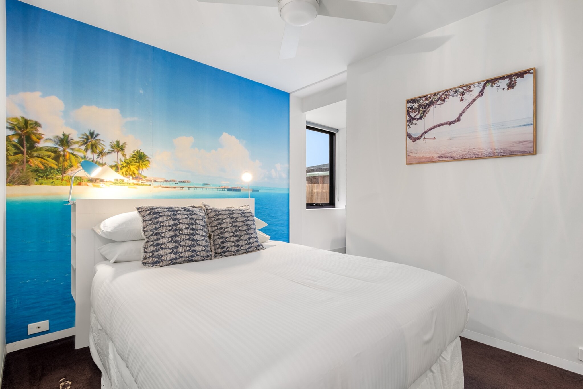 Located in the heart of Melbourne, this chic 2-bedroom, 2-bathroom apartment is perfect for up to 4 guests seeking a comfortable city retreat. Both stylish and practical, the space features blackout blinds, ceiling fans, and thoughtfully designed interiors. With easy access to vibrant cafes, cultural attractions, and shopping precincts, it’s a gateway to everything Melbourne has to offer. Enjoy the convenience of self-check-in for a seamless stay in this dynamic city.
The space
Step into a sleek and inviting space that perfectly balances comfort and style. This apartment boasts two spacious bedrooms, each fitted with queen beds, built-in bedside tables, and blackout blinds for restful nights. Both rooms feature ceiling fans for added comfort. The living area is designed for relaxation, with a 4-seater couch and a TV offering Free-to-Air channels and streaming options. The modern kitchen is fully equipped, while the dining area seats four, making it perfect for shared meals. Both bathrooms are en-suites, offering privacy and convenience. With easy access to Melbourne’s lively streets, this apartment is an ideal urban escape.
Living Room
-Couch seats 4 people
-TV with Free-to-Air channels and streaming options (guests to use their own credentials)
Kitchen & Dining Area
-Fully equipped with cutlery and utensils
-Oven and electric stovetop
-Dining area seats 4
Bathroom & Laundry
-Ensuites with both bedrooms
-Laundry room available with washer and dryer combo
-Travel essentials, towels, and hairdryer provided
Amenity Notes
-Ceiling fans in both bedrooms
-Split system air conditioning in the living area
-Wi-Fi available
-Private balcony with seating for 2
-Paid off-street parking (Russell St)