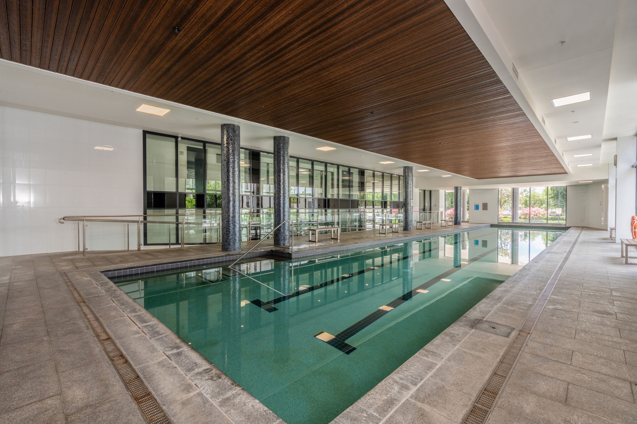 Enjoy a relaxing stay at this 2-bed, 2-bath apartment in Lyneham. Featuring spacious interiors, a private balcony, and blackout blinds, itâ€™s perfect for families or business travellers. The underground parking ensures convenience, while self-check-in adds flexibility. Located near cafÃ©s, shops, and transport, with the tram just across the road, this apartment provides easy access to Canberraâ€™s attractions.
The space
Step into this inviting 2-bedroom, 2-bathroom apartment, where comfort meets functionality. The master bedroom boasts a plush queen bed, blackout blinds, and an en-suite, while the second bedroom also features a queen bed and ample storage. The open-plan living area is filled with natural light and offers a 5-seater couch, a TV with free-to-air channels, and access to a private balconyâ€”perfect for unwinding. The fully equipped kitchen includes an oven, electric stovetop, and a dining table for four, ideal for preparing and sharing meals. With a second bathroom and in-unit laundry facilities, every detail is designed to ensure a convenient and relaxing stay.
 
Living Room
-Couch seats 5 people
-TV with streaming options (guests to use their own credentials)
 
Kitchen & Dining Area
-Fully equipped with cutlery and utensils
-Oven and electric stovetop
-Dining area seats 4 people
 
Bathroom & Laundry
-Laundry room available with washer and dryer
-Travel essentials, towels, and hairdryer provided
 
Amenity Notes
-Underground parking for 2 cars with a 2.1m height restriction
-Wi-Fi is available
-Private balcony with outdoor seating
-Air conditioning in lounge room and main bedroom
-Access to communal indoor pool, communal BBQ area, gym, and garden
Local area description
Located in vibrant Lyneham, this apartment offers access to Canberra's highlights. Explore nearby cafÃ©s, boutiques, and parks, or visit the renowned Canberra City Centre just a short drive away. The tranquil setting combines urban convenience with leafy surroundings, ideal for both leisure and business stays.
House rules
You are staying in a friendly and peaceful neighbourhood and we kindly ask you to respect the community and your surrounding neighbours. The following strict House Rules apply:
 
- No loud noise between 10 pm and 8 am
- No parties or antisocial behaviour
- No additional people are to access the property without our prior approval
- No pets are allowed in the property without approval
- No smoking is allowed at any times
- If you break something, please let us know
- To help protect all floor coverings, do not wear any shoes inside the property
 
Please be aware that excessive noise such as amplified music, vocals or screaming or anti-social behaviour in the property or common areas can cause neighbours to complain to us, the Building Manager, Council Rangers or Police.
 
IMPORTANT:
- Any breach of the House Rules may lead to a $500 fine plus compensation for any cost/damage created and immediate eviction of the property without refund.
- Pets are available on request unless the property states it is pet friendly. Any stays with pets will incur an additional cleaning fee of $200.
 
Finally, when checking out, we kindly ask you for the following:
 
- Please leave all beds unmade
- Please clean up your dishes and put them away
- In case you have rearranged furniture, please put it back to the original location
- Please take out the rubbish and remember to use the right bins
- Please ensure all appliances, A/C and lights are off and doors and windows are closed.
- Please check your accommodation thoroughly before departing to avoid any unintentional items left behind.
 
We are not liable for any items left behind after your stay. In the rare event that a guest reports a missing item, we will make every effort to locate it for you, but we cannot guarantee its retrieval. If the item is found, we will gladly assist in arranging its return to an address within Australia, subject to postage and service fees.
Interaction with guests
Welcome to MadeComfy! Our local team curates stays in exceptional Australian & New Zealand properties, ensuring style, comfort, and prime locations for discerning guests. We prioritise your needs to provide a memorable home-away-from-home experience. Explore our digital guidebooks for local recommendations, and don't hesitate to contact us throughout your stay. We're here to ensure your comfort - enjoy your stay with MadeComfy.
Notes
For your comfort, this property is prepared with professional-grade hotel-style linen, including a three-sheet setup, ensuring a fresh and hygienic sleep experience.
 
Extra Services:
- Early Check-in: Our standard check-in is at 3 pm. To guarantee early access to the property we suggest booking the night before if available. Otherwise, early check-in is subject to availability from the night before at an additional cost.
- Late check-out: Our standard check-out is at 10 am. To guarantee a later check-out of the property we suggest booking an additional night if available. Otherwise, a late check-out is subject to availability from the night before to an additional cost.
- Baggage: For security reasons, we are unable to receive or to keep unattended baggage before check-in or after check-out
- We provide a small welcome amenity pack to get your stay started.
- This booking is protected with coverage for lost baggage and emergency medical expenses, provided by Travel Support with claim upto 500 AUD (T&C Applies). For more details reach out to Guest Support team post booking.
Access description
The key collection is located offsite,400 meters from the property and not available 24/7. Further details will be provided 3 days before check-in if your booking is successfully reserved.
Getting around
Public Transport: Bus stops within a 5-min walk provide routes across Canberra, including the city centre.
 
Getting There: Canberra Airport is a 15-min drive. The city centre is 10 mins by car or public transport.
