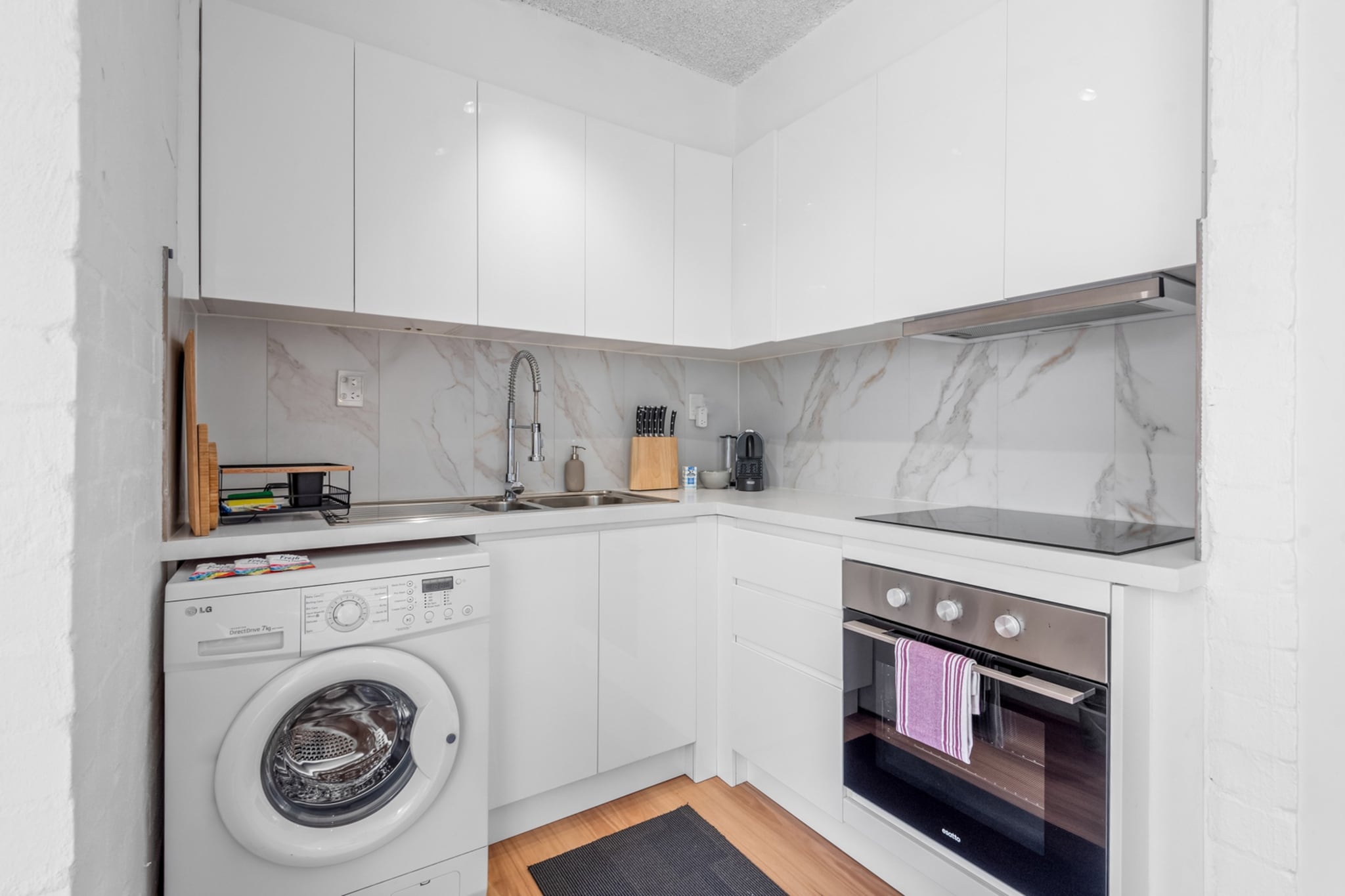 Unwind in this chic and cosy 1-bedroom, 1-bathroom apartment, perfectly positioned in South Yarra’s vibrant hub. Designed with comfort and convenience in mind, it features a comfy living space, a well-equipped kitchen, and blackout blinds for the ultimate sleep-in. With easy self-check-in and steps away from Melbourne’s best shopping, dining, and cultural hot spots, this retreat is ideal for solo travellers or couples chasing a city escape.
The space
This delightful 1-bedroom, 1-bathroom apartment is your private oasis in South Yarra. The bedroom features a comfortable queen-sized bed, blackout blinds for a restful sleep, and ample storage space for your belongings. The living area invites relaxation with a cosy two-seater couch and TV—perfect for unwinding after a day of exploration. Adjacent to the living area, the dining space comfortably seats two and flows into a fully equipped kitchen, complete with an electric stovetop, oven, and all the essentials you need to prepare your favourite meals. For your convenience, the apartment includes a private laundry area with a washer and dryer, ensuring a hassle-free stay.
Living Room
-Comfortable two-seater couch
-TV with Free-to-Air and streaming options (available with your own login).
Kitchen & Dining Area
-Fully equipped kitchen with all the essentials
-Oven and electric stovetop
-Dining space designed for two, whether morning coffee or a romantic dinner.
Bathroom & Laundry
-Sparkling clean bathroom with towels, travel essentials, and a hairdryer provided.
-Washer and dryer combo available for your convenience (located in the kitchen)
Amenity Notes
-Complimentary Wi-Fi to keep you connected
-A/C in the living area
-Portable heater in the bedroom for year-round comfort.
-Onsite parking available.