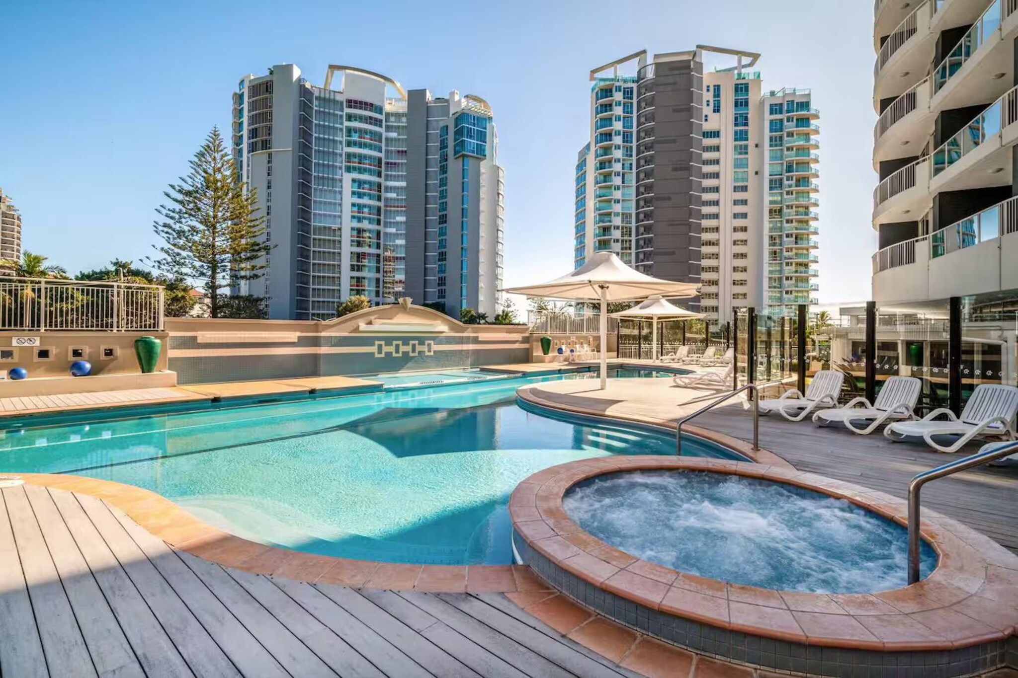Experience a comfortable stay in this stylish 1-bedroom apartment in Mantra Twin Towns Resort. Offering coastal charm, this space is perfect for solo travellers or couples. Enjoy access to a gym, pool, sauna, and a games room, plus a private balcony with outdoor seating. Conveniently located near shops and beaches, the apartment includes on-site parking, ducted air conditioning, and a private laundry. With easy transport options nearby, it’s an ideal base for exploring the Gold Coast and beyond.
The space
Unwind in this boutique 1-bedroom apartment in the heart of Tweed Heads, offering a stylish retreat with a serene coastal vibe. The spacious bedroom features a plush king bed, blackout blinds, and climate control for ultimate comfort. The light-filled open-plan living area extends to a generous balcony, perfect for enjoying the fresh ocean air. With modern amenities, including air conditioning and heating throughout, this apartment is an ideal escape near beaches, cafés, and entertainment hubs.
 
Enjoy access to premium building amenities, including a heated indoor and outdoor swimming pool, sauna, gym, mini golf course, games room, two tennis courts, and an outdoor BBQ area. Located within the renowned Mantra Twin Towns, you’re just a short stroll from the Twin Towns Services Club, where you can catch live music, entertainment, and a variety of dining options seven days a week.
 
Only moments away, you'll find the iconic Greenmount Beach and beautiful Rainbow Bay, perfect for a swim or a scenic walk along Marine Parade. With beaches, cafés, and transport links at your doorstep, this apartment is an ideal choice for a memorable stay in Tweed Heads.
 
Living Room
-Couch seats 2 people
-TV with Foxtel (guests to use their own credentials)
 
Kitchen & Dining Area
-Fully equipped with cutlery and utensils
-Oven and electric stovetop
-Dining area seats 2
 
Bathroom & Laundry
-Laundry room available with washer and dryer
-Travel essentials, towels, and hairdryer provided
 
Amenity Notes
-On-site underground parking (height restriction: 2.2m)
-Ducted A/C (heating + cooling) throughout
-Private balcony with outdoor seating
-Building amenities: gym, pool, sauna, terrace, games room
Local area description
Tweed Heads is a vibrant coastal town offering beautiful beaches, lively dining spots, and scenic riverfront walks. Relax at Coolangatta Beach, take in the views from Point Danger Lookout, or enjoy fresh seafood at the local restaurants. Just minutes from the Gold Coast, this destination is perfect for beach lovers and adventure seekers alike.
House rules
You are staying in a friendly and peaceful neighbourhood and we kindly ask you to respect the community and your surrounding neighbours. The following strict House Rules apply:
 
- No loud noise between 10 pm and 8 am
- No parties or antisocial behaviour
- No additional people are to access the property without our prior approval
- No pets are allowed in the property without approval
- No smoking is allowed at any times
- If you break something, please let us know
- To help protect all floor coverings, do not wear any shoes inside the property
 
Please be aware that excessive noise such as amplified music, vocals or screaming or anti-social behaviour in the property or common areas can cause neighbours to complain to us, the Building Manager, Council Rangers or Police.
 
IMPORTANT:
- Any breach of the House Rules may lead to a $500 fine plus compensation for any cost/damage created and immediate eviction of the property without refund.
- Pets are available on request unless the property states it is pet friendly. Any stays with pets will incur an additional cleaning fee of $200.
 
Finally, when checking out, we kindly ask you for the following:
 
- Please leave all beds unmade
- Please clean up your dishes and put them away
- In case you have rearranged furniture, please put it back to the original location
- Please take out the rubbish and remember to use the right bins
- Please ensure all appliances, A/C and lights are off and doors and windows are closed.
- Please check your accommodation thoroughly before departing to avoid any unintentional items left behind.
 
We are not liable for any items left behind after your stay. In the rare event that a guest reports a missing item, we will make every effort to locate it for you, but we cannot guarantee its retrieval. If the item is found, we will gladly assist in arranging its return to an address within Australia, subject to postage and service fees.
Interaction with guests
Welcome to MadeComfy! Our local team curates stays in exceptional Australian & New Zealand properties, ensuring style, comfort, and prime locations for discerning guests. We prioritise your needs to provide a memorable home-away-from-home experience. Explore our digital guidebooks for local recommendations, and don't hesitate to contact us throughout your stay. We're here to ensure your comfort - enjoy your stay with MadeComfy.
Notes
For your comfort, this property is prepared with professional-grade hotel-style linen, including a three-sheet setup, ensuring a fresh and hygienic sleep experience.
 
Extra Services:
- Early Check-in: Our standard check-in is at 3 pm. To guarantee early access to the property we suggest booking the night before if available. Otherwise, early check-in is subject to availability from the night before at an additional cost.
- Late check-out: Our standard check-out is at 10 am. To guarantee a later check-out of the property we suggest booking an additional night if available. Otherwise, a late check-out is subject to availability from the night before to an additional cost.
- Baggage: For security reasons, we are unable to receive or to keep unattended baggage before check-in or after check-out
- We provide a small welcome amenity pack to get your stay started.
- This booking is protected with coverage for lost baggage and emergency medical expenses, provided by Travel Support with claim upto 500 AUD (T&C Applies). For more details reach out to Guest Support team post booking.
Access description
The key collection is offsite. Further details will be provided 3 days before check-in if your booking is successfully reserved.
Getting around
Public Transport: Tweed Heads offers bus services connecting to Gold Coast and surrounding suburbs, with the nearest stop at Tweed Mall Bus Station.
 
Getting There: The apartment is a 10-minute drive from Gold Coast Airport and a 1-hour drive from Brisbane CBD.