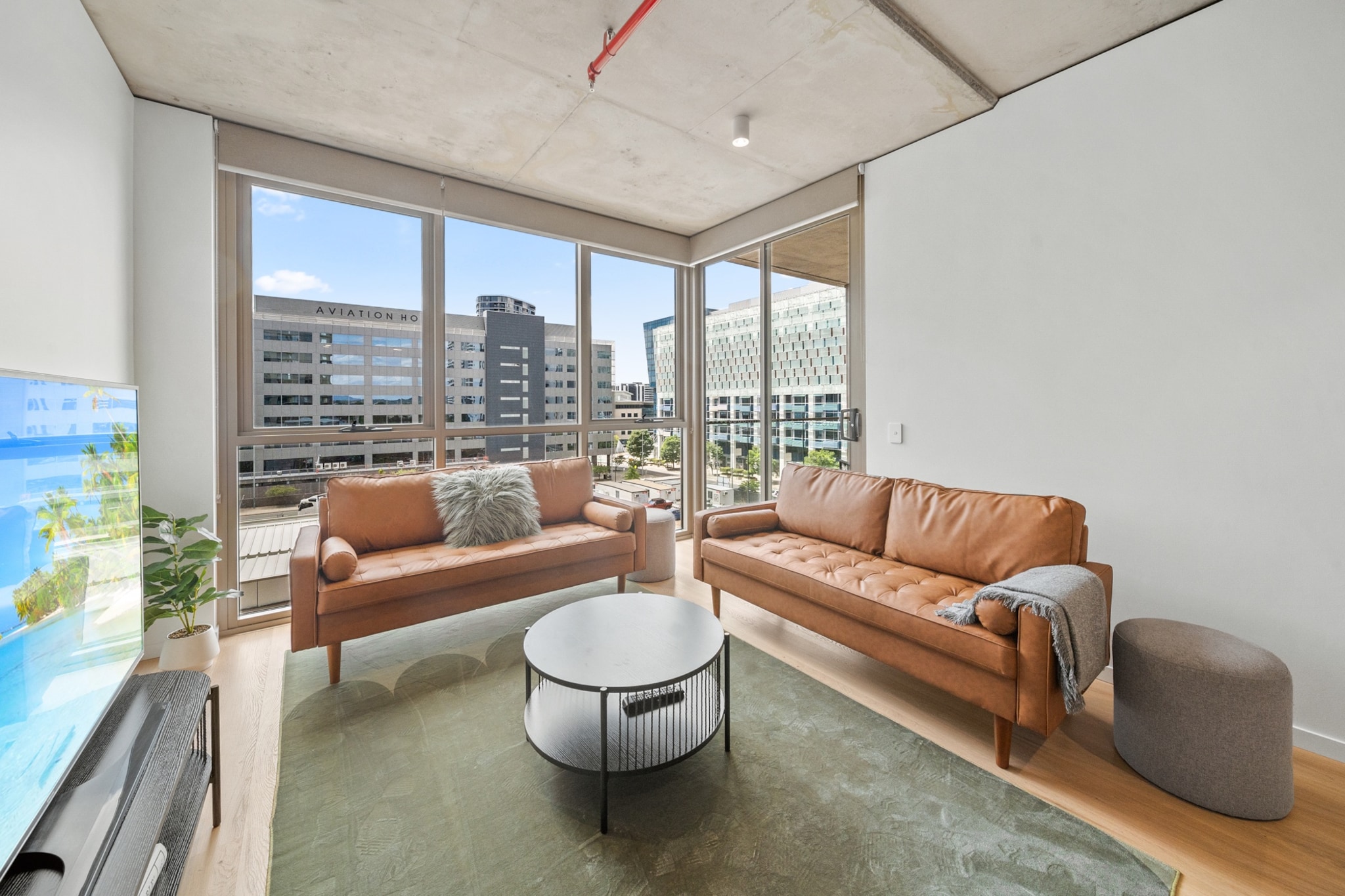 Experience comfort and convenience in this modern 2-bedroom apartment in Phillip. Featuring a bright open-plan layout, a private balcony, and secure underground parking, it’s perfect for business or leisure stays. Enjoy access to the building’s gym, BBQ area, and pool. Located close to local shops, dining, and transport, this stylish retreat offers everything needed for a relaxing stay.
The space
This spacious 2-bedroom apartment blends style and practicality, offering a comfortable retreat in the heart of Phillip. The open-plan living area is bathed in natural light, featuring a plush 4-seater couch, a TV with streaming options, and elegant décor. The fully equipped kitchen includes an electric stovetop, oven, and dining area for four, with additional seating at the countertop. The two queen-sized bedrooms offer restful nights with blackout blinds and ample storage. The main bedroom boasts an ensuite for added privacy. A second bathroom, complete with essentials, ensures convenience for all guests. Step out onto the balcony, accessible from both the living area and the main bedroom, for a breath of fresh air. Guests also enjoy access to the building’s gym, BBQ area, and pool, making it a perfect choice for a comfortable and enjoyable stay.
Living Room
-Two couches seat 7 people
-TV with free-to-air and streaming (guests to use their own credentials)
Kitchen & Dining Area
-Fully equipped with cutlery and utensils
-Oven and electric stovetop
-Dining area seats 4 and countertop seats 2
Bathroom & Laundry
-Laundry room available with washer and dryer
-Travel essentials, towels, and hairdryer provided
Amenity Notes
-Onsite underground parking for 1 car (height restriction: 2.2m)
-Wall-mounted air conditioning in bedrooms and living area
-Wi-Fi is available
-Private balcony with seating for 2 (off the living area and main bedroom)
-Access to building amenities: gym, pool (ground floor), BBQ area (level 11)
Local area description
Phillip is a vibrant suburb of Canberra, offering a mix of convenience and leisure. The area is home to Westfield Woden, a major shopping hub with a variety of dining and retail options. Enjoy the nearby Eddison Park for outdoor activities, or visit the National Arboretum for scenic views and gardens. With excellent public transport links, it’s easy to explore Canberra’s attractions while staying in this well-connected location.
House rules
You are staying in a friendly and peaceful neighbourhood and we kindly ask you to respect the community and your surrounding neighbours. The following strict House Rules apply:
- No loud noise between 10 pm and 8 am
- No parties or antisocial behaviour
- No additional people are to access the property without our prior approval
- No pets are allowed in the property without approval
- No smoking is allowed at any times
- If you break something, please let us know
- To help protect all floor coverings, do not wear any shoes inside the property
Please be aware that excessive noise such as amplified music, vocals or screaming or anti-social behaviour in the property or common areas can cause neighbours to complain to us, the Building Manager, Council Rangers or Police.
IMPORTANT:
- Any breach of the House Rules may lead to a $500 fine plus compensation for any cost/damage created and immediate eviction of the property without refund.
- Pets are available on request unless the property states it is pet friendly. Any stays with pets will incur an additional cleaning fee of $200.
Finally, when checking out, we kindly ask you for the following:
- Please leave all beds unmade
- Please clean up your dishes and put them away
- In case you have rearranged furniture, please put it back to the original location
- Please take out the rubbish and remember to use the right bins
- Please ensure all appliances, A/C and lights are off and doors and windows are closed.
- Please check your accommodation thoroughly before departing to avoid any unintentional items left behind.
We are not liable for any items left behind after your stay. In the rare event that a guest reports a missing item, we will make every effort to locate it for you, but we cannot guarantee its retrieval. If the item is found, we will gladly assist in arranging its return to an address within Australia, subject to postage and service fees.
Interaction with guests
Welcome to MadeComfy! Our local team curates stays in exceptional Australian & New Zealand properties, ensuring style, comfort, and prime locations for discerning guests. We prioritise your needs to provide a memorable home-away-from-home experience. Explore our digital guidebooks for local recommendations, and don't hesitate to contact us throughout your stay. We're here to ensure your comfort - enjoy your stay with MadeComfy.
Notes
For your comfort, this property is prepared with professional-grade hotel-style linen, including a three-sheet setup, ensuring a fresh and hygienic sleep experience.
Extra Services:
- Early Check-in: Our standard check-in is at 3 pm. To guarantee early access to the property we suggest booking the night before if available. Otherwise, early check-in is subject to availability from the night before at an additional cost.
- Late check-out: Our standard check-out is at 10 am. To guarantee a later check-out of the property we suggest booking an additional night if available. Otherwise, a late check-out is subject to availability from the night before to an additional cost.
- Baggage: For security reasons, we are unable to receive or to keep unattended baggage before check-in or after check-out
- We provide a small welcome amenity pack to get your stay started.
- This booking is protected with coverage for lost baggage and emergency medical expenses, provided by Travel Support with claim upto 500 AUD (T&C Applies). For more details reach out to Guest Support team post booking.
Access description
- Key collection is onsite. Further details will be provided 3 days before check-in if your booking is successfully reserved.
- There is a construction site nearby and excessive noise may be present.
Getting around
Public Transport
Phillip is well-serviced by bus routes connecting to Woden Interchange, Canberra CBD, and surrounding suburbs.
Getting There
The property is about a 15-minute drive from Canberra Airport and 10 minutes from Canberra’s city centre.