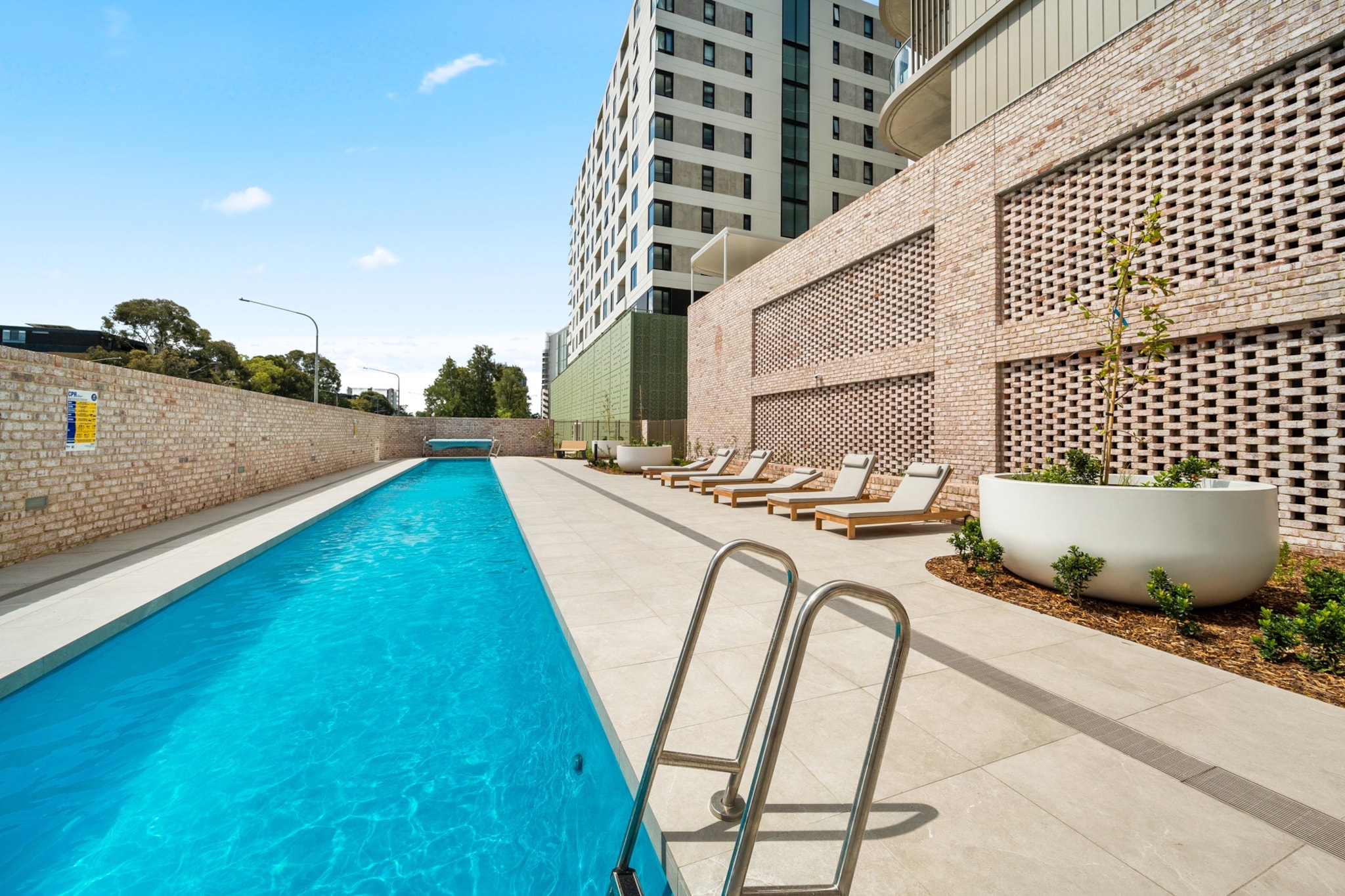 Bed Linen, Desk, Elevator, Hot Water, Internet Access DSL, Wardrobe, Living room(TV, seating area), Kitchen(dining table, stove, electric kettle, toaster, coffee machine, oven, microwave, dishwasher, fridge, dishes and cutlery), bedroom(Queen Bed), bedroom(Queen Bed), bathroom(shower, washbasin, toilet, hairdryer, Towels/Sheets (Incl.), Essentials), bathroom(shower, washbasin, toilet, hairdryer, Towels incl., Essentials), First Aid, Play area, tumble dryer, washing machine, balcony or terrace, heating, air conditioning, swimming pool, private outdoor pool, iron, Dedicated workspace, Long term stays allowed, Mountain view, Room-darkening shades, Town, Wine glasses