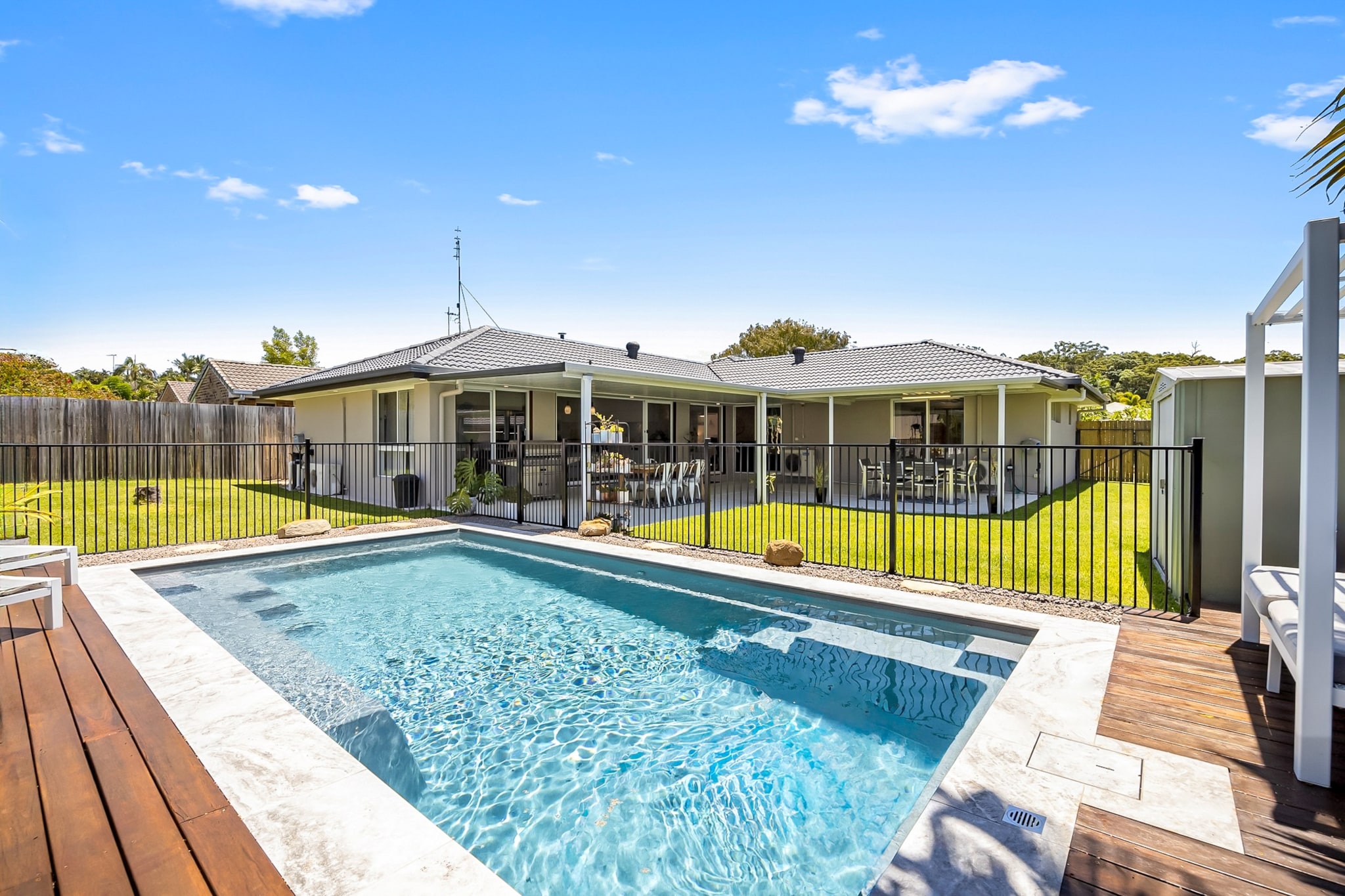 Escape to this spacious 3-bedroom home in Buderim, perfect for families or groups. Featuring a private pool, outdoor fire pit, and a fully equipped BBQ, itâ€™s ideal for relaxation and entertainment. Enjoy air conditioning in key areas, ceiling fans in all bedrooms, and Wi-Fi access. With convenient driveway parking and a study nook, this peaceful retreat is close to local shops, parks, and beaches for a memorable getaway.
The space
This inviting 3-bedroom, 2-bathroom house offers a warm and spacious retreat for up to six guests. The main bedroom features a king-sized bed and an en-suite bathroom, while the two other bedrooms are equipped with queen-sized beds and ceiling fans for comfort. Relax in the stylish living area, furnished with a plush 6-seater couch and a TV with streaming. The kitchen is fully equipped with an electric stovetop, oven, dishwasher, and all essential utensils, complemented by a dining table that seats five and a countertop seating area with three stools. A private laundry room includes a washer, ironing board, and drying rack for convenience. Outside, enjoy a sparkling pool, a fire pit, and a BBQ on the patio. The driveway offers parking for two cars, with additional street parking available. A study nook is situated near the front door for guests needing a workspace.
 
Living Room
-Couch seats 6 people
-Lounge room seats 2 people
-TV's with streaming services (guests to use credentials)
 
Kitchen & Dining Area
-Fully equipped with cutlery and utensils
-Electric stovetop and oven
-Dining area seats 5 & countertop seats 3
 
Bathroom & Laundry
-Laundry room with washer and ironing board
-Travel essentials, towels, and hairdryer provided
 
Amenity Notes
-Wi-Fi is available
-Reverse cycle A/C in master bedroom, living, and family rooms
-Ceiling fans in all bedrooms
-Driveway parking for 2 cars
-Study room with printer available
-Private pool with loungers
-Outdoor fire pit and gas BBQ
-Two outdoor dining seats 6 each
Local area description
Buderim offers a tranquil lifestyle on Queensland's Sunshine Coast, surrounded by lush greenery, cafes, and scenic views. Explore Buderim Forest Parkâ€™s serene walking trails or enjoy the charm of the Buderim Village with its shops and markets. The pristine Mooloolaba Beach, a short drive away, is perfect for a day of swimming or dining at waterfront restaurants.
House rules
You are staying in a friendly and peaceful neighbourhood and we kindly ask you to respect the community and your surrounding neighbours. The following strict House Rules apply:
 
- No loud noise between 10 pm and 8 am
- No parties or antisocial behaviour
- No additional people are to access the property without our prior approval
- No pets are allowed in the property without approval
- No smoking is allowed at any times
- If you break something, please let us know
- To help protect all floor coverings, do not wear any shoes inside the property
 
Please be aware that excessive noise such as amplified music, vocals or screaming or anti-social behaviour in the property or common areas can cause neighbours to complain to us, the Building Manager, Council Rangers or Police.
 
IMPORTANT:
- Any breach of the House Rules may lead to a $500 fine plus compensation for any cost/damage created and immediate eviction of the property without refund.
- Pets are available on request unless the property states it is pet friendly. Any stays with pets will incur an additional cleaning fee of $200.
 
Finally, when checking out, we kindly ask you for the following:
 
- Please leave all beds unmade
- Please clean up your dishes and put them away
- In case you have rearranged furniture, please put it back to the original location
- Please take out the rubbish and remember to use the right bins
- Please ensure all appliances, A/C and lights are off and doors and windows are closed.
- Please check your accommodation thoroughly before departing to avoid any unintentional items left behind.
 
We are not liable for any items left behind after your stay. In the rare event that a guest reports a missing item, we will make every effort to locate it for you, but we cannot guarantee its retrieval. If the item is found, we will gladly assist in arranging its return to an address within Australia, subject to postage and service fees.
Interaction with guests
Welcome to MadeComfy! Our local team curates stays in exceptional Australian & New Zealand properties, ensuring style, comfort, and prime locations for discerning guests. We prioritise your needs to provide a memorable home-away-from-home experience. Explore our digital guidebooks for local recommendations, and don't hesitate to contact us throughout your stay. We're here to ensure your comfort - enjoy your stay with MadeComfy.
Notes
- For your comfort, this property is prepared with professional-grade hotel-style linen, including a three-sheet setup, ensuring a fresh and hygienic sleep experience.
- Please note that the garage is not included.
 
Extra Services:
- Early Check-in: Our standard check-in is at 3 pm. To guarantee early access to the property we suggest booking the night before if available. Otherwise, early check-in is subject to availability from the night before at an additional cost.
- Late check-out: Our standard check-out is at 10 am. To guarantee a later check-out of the property we suggest booking an additional night if available. Otherwise, a late check-out is subject to availability from the night before to an additional cost.
- Baggage: For security reasons, we are unable to receive or to keep unattended baggage before check-in or after check-out
- We provide a small welcome amenity pack to get your stay started.
- This booking is protected with coverage for lost baggage and emergency medical expenses, provided by Travel Support with claim upto 500 AUD (T&C Applies). For more details reach out to Guest Support team post booking.
Access description
Key collection is onsite. Further details will be provided 3 days before check-in if your booking is successfully reserved.
A storage room will be blocked off and no access for guests
Getting around
Public Transport: Buderim is serviced by local bus routes connecting to Sunshine Plaza and Maroochydore.
 
Getting There: Approximately 15 km (20-minute drive) from Sunshine Coast Airport.