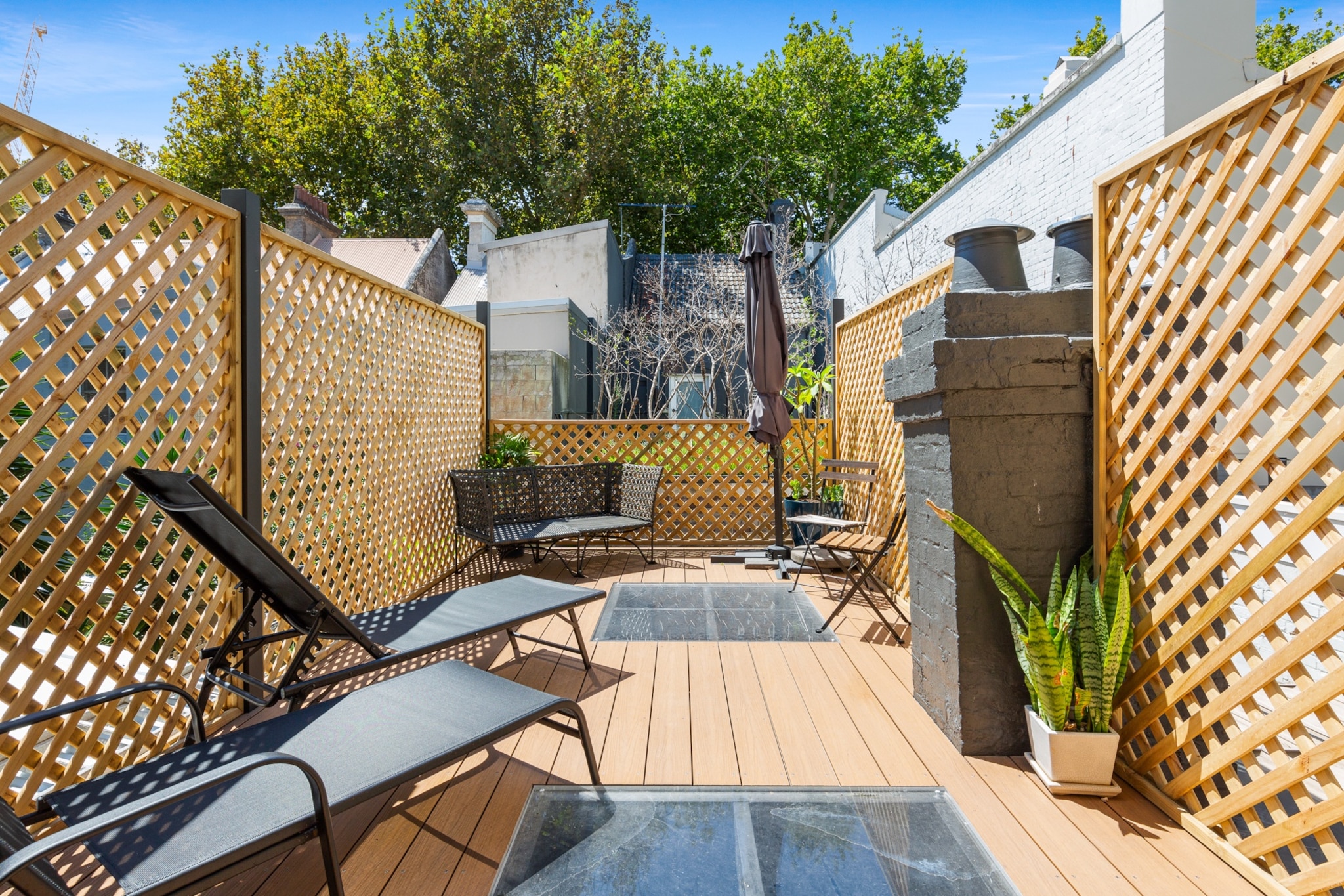 Experience the charm of this elegant 2-bedroom terrace in the heart of Darlinghurst. With a spacious living area, private courtyard, and rooftop deck, it offers a stylish retreat for up to 4 guests. The fully equipped kitchen, comfortable bedrooms, and modern conveniences ensure a relaxing stay. Enjoy easy access to local cafÃ©s, shops, and transport, all while unwinding in a beautifully styled home with seamless self-check-in.
The space
This beautifully designed 2-bedroom terrace home offers a sophisticated inner-city retreat. The living area features a comfortable 4-seater couch and a TV with free-to-air and streaming apps. The fully equipped kitchen includes an induction stovetop, electric oven, and a dining area that seats four, with an additional two seats at the countertop. Both bedrooms feature ceiling fans and quality bedding, ensuring a restful stay. A private rooftop deck and a charming courtyard provide outdoor relaxation spaces. The home also includes a laundry with a washer and dryer, and guests can enjoy seamless Wi-Fi access. With stylish interiors and thoughtful amenities, this home is perfect for business travellers, couples, or small groups looking to experience the best of Sydney.
 
Living Room:
-Couch seats 4 people
-TV with free-to-air and streaming apps (guests to use their own credentials)
 
Kitchen & Dining Area:
-Fully equipped with cutlery and utensils
-Oven and induction stovetop
-Dining area seats 4 and countertop seats 2
 
Bathroom & Laundry:
-Laundry room available with washer and dryer
-Travel essentials, towels, and hairdryer provided
 
Amenity Notes:
-Wi-Fi is available
-Ceiling fans in bedrooms
-Gas heaters on the property
-Private rooftop deck loungers and parasol
-Outdoor courtyard with seating for 4
-Study nook on the middle floor
-No Parking
Local area description
Darlinghurst is a lively inner-city suburb known for its trendy cafÃ©s, bars, and boutique shopping. Enjoy a vibrant arts scene with galleries and theatres, or take a short walk to Hyde Park and Oxford Street. Iconic attractions like the Royal Botanic Gardens, Sydney Opera House, and Darling Harbour are just minutes away, offering a perfect mix of urban excitement and green spaces.
House rules
You are staying in a friendly and peaceful neighbourhood and we kindly ask you to respect the community and your surrounding neighbours. The following strict House Rules apply:
 
- No loud noise between 10 pm and 8 am
- No parties or antisocial behaviour
- No additional people are to access the property without our prior approval
- No pets are allowed in the property without approval
- No smoking is allowed at any times
- If you break something, please let us know
- To help protect all floor coverings, do not wear any shoes inside the property
 
Please be aware that excessive noise such as amplified music, vocals or screaming or anti-social behaviour in the property or common areas can cause neighbours to complain to us, the Building Manager, Council Rangers or Police.
 
IMPORTANT:
- Any breach of the House Rules may lead to a $500 fine plus compensation for any cost/damage created and immediate eviction of the property without refund.
- Pets are available on request unless the property states it is pet friendly. Any stays with pets will incur an additional cleaning fee of $200.
 
Finally, when checking out, we kindly ask you for the following:
 
- Please leave all beds unmade
- Please clean up your dishes and put them away
- In case you have rearranged furniture, please put it back to the original location
- Please take out the rubbish and remember to use the right bins
- Please ensure all appliances, A/C and lights are off and doors and windows are closed.
- Please check your accommodation thoroughly before departing to avoid any unintentional items left behind.
 
We are not liable for any items left behind after your stay. In the rare event that a guest reports a missing item, we will make every effort to locate it for you, but we cannot guarantee its retrieval. If the item is found, we will gladly assist in arranging its return to an address within Australia, subject to postage and service fees.
Interaction with guests
Welcome to MadeComfy! Our local team curates stays in exceptional Australian & New Zealand properties, ensuring style, comfort, and prime locations for discerning guests. We prioritise your needs to provide a memorable home-away-from-home experience. Explore our digital guidebooks for local recommendations, and don't hesitate to contact us throughout your stay. We're here to ensure your comfort - enjoy your stay with MadeComfy.
Notes
- For your comfort, this property is prepared with professional-grade hotel-style linen, including a three-sheet setup, ensuring a fresh and hygienic sleep experience.
- There is ongoing construction near this property, and you may experience some noise during your stay.
 
Extra Services:
- Early Check-in: Our standard check-in is at 3 pm. To guarantee early access to the property we suggest booking the night before if available. Otherwise, early check-in is subject to availability from the night before at an additional cost.
- Late check-out: Our standard check-out is at 10 am. To guarantee a later check-out of the property we suggest booking an additional night if available. Otherwise, a late check-out is subject to availability from the night before to an additional cost.
- Baggage: For security reasons, we are unable to receive or to keep unattended baggage before check-in or after check-out
- We provide a small welcome amenity pack to get your stay started.
- This booking is protected with coverage for lost baggage and emergency medical expenses, provided by Travel Support with claim upto 500 AUD (T&C Applies). For more details reach out to Guest Support team post booking.
Access description
Key collection is onsite. Further details will be provided 3 days before check-in if your booking is successfully reserved.
Getting around
Public Transport:
Bus routes and train services from Kings Cross Station connect to the city, Bondi, and beyond.
 
Getting There:
Sydney Airport is a 20-minute drive away, while the Sydney CBD is just a 10-minute trip by public transport or car.