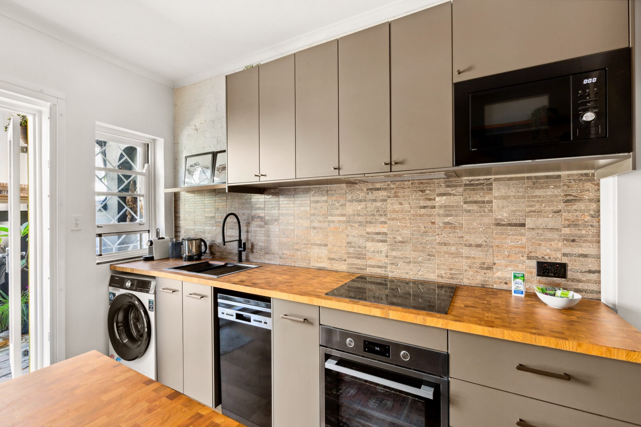 Stylish Inner-City Terrace Home with Rooftop Deck