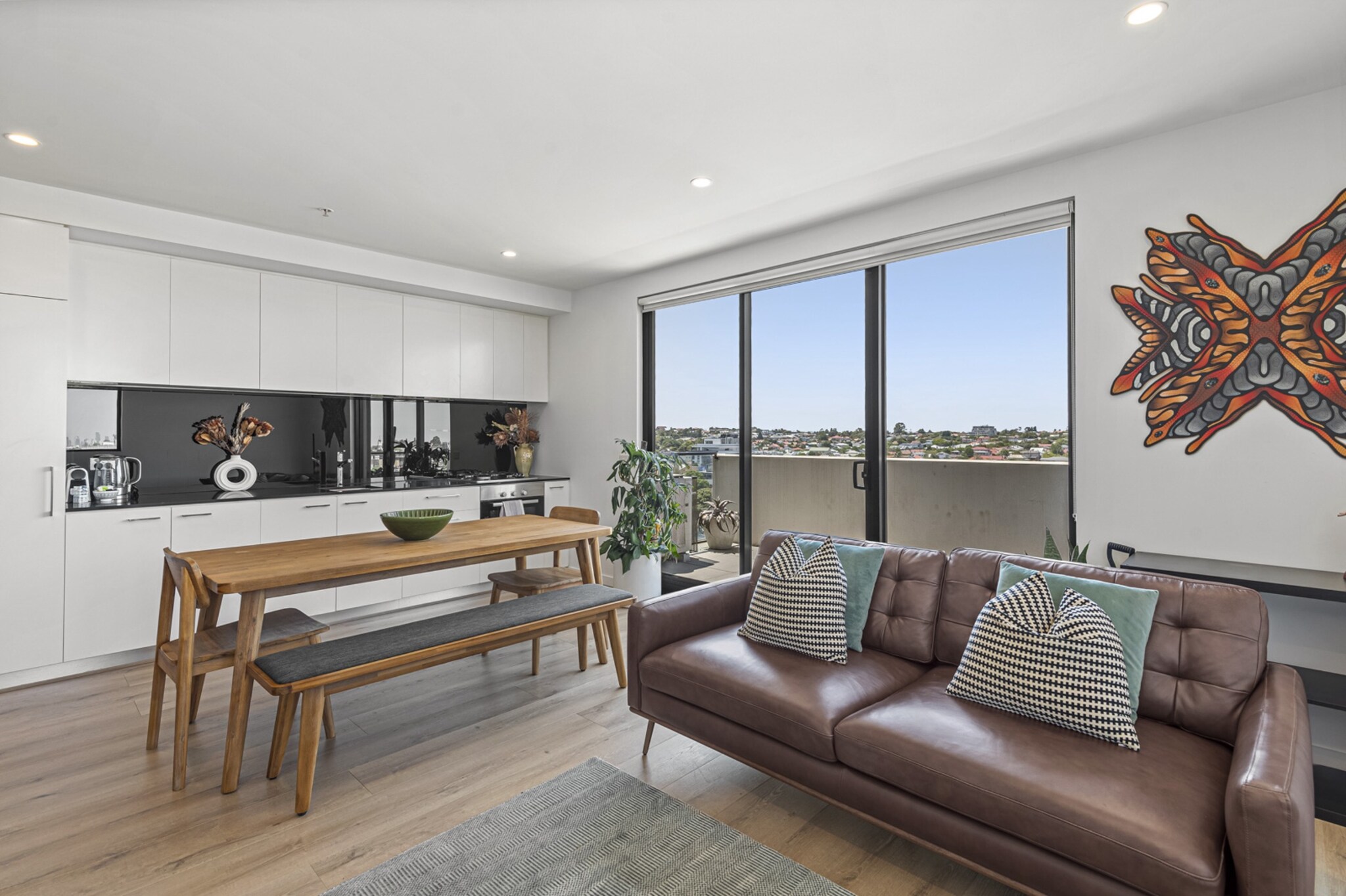 Discover a stylish 2-bed, 2-bath apartment in the heart of Preston. Featuring a king bed, a comfortable sofa bed, and two private balconies, this bright retreat is perfect for business or leisure stays. Enjoy a fully equipped kitchen, a cosy living area, and easy access to public transport, shops, and dining. With Wi-Fi, in-unit laundry, and modern amenities, this urban escape offers both comfort and convenience.
The space
Step into a bright and contemporary 2-bedroom apartment designed for comfort and convenience. The master bedroom features a plush king bed with blackout blinds, while the second sleeping area includes a cosy sofa bed, perfect for additional guests. The open-plan living space flows seamlessly into a fully equipped kitchen with a gas stovetop, an electric oven, and a dining area that seats five. Relax in the inviting lounge with a three-seater couch and a TV with free-to-air channels, or step onto one of two private balconies to enjoy city views. The sleek bathroom includes essential amenities and a hairdryer. A private laundry with a washer and dryer adds to the convenience. Situated close to public transport, shops, and dining, this stylish retreat is the perfect urban escape.
 
Living Room:
-Couch seats 3 people
-TV with free-to-air channels and streaming options (guests to use their own credentials)
 
Kitchen & Dining Area:
-Fully equipped with cutlery and utensils
-Oven and gas stovetop
-Dining area seats 5
 
Bathroom & Laundry:
-Laundry room available with washer and dryer
-Travel essentials, towels, and hairdryer provided
 
Amenity Notes:
-No parking
-Air conditioning in the living room
-Heater in the living room
-Fan in the bedroom
-Wi-Fi is available
-Two private balconies with outdoor furniture