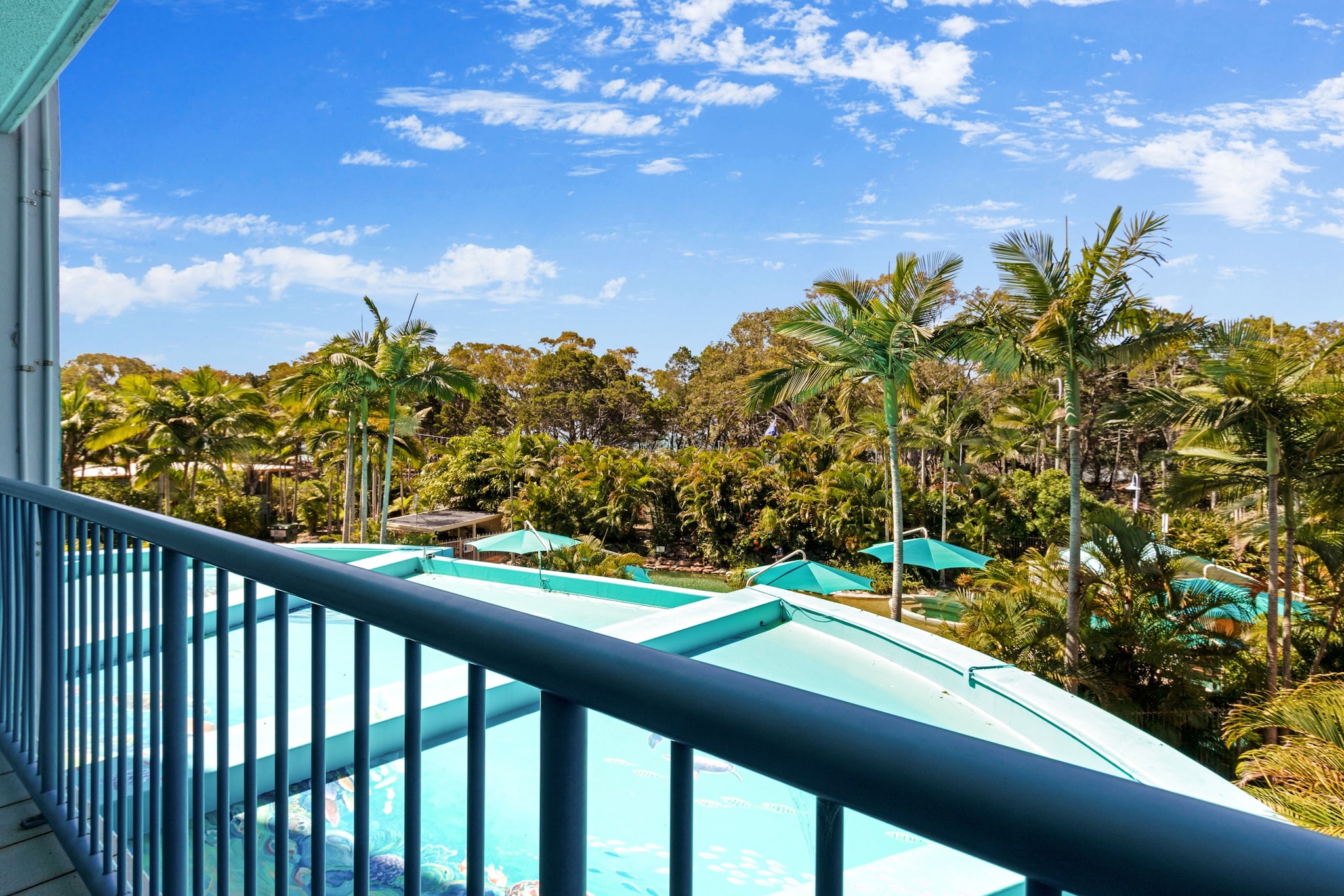 Resort-Style Stay with Balcony & Garage Parking