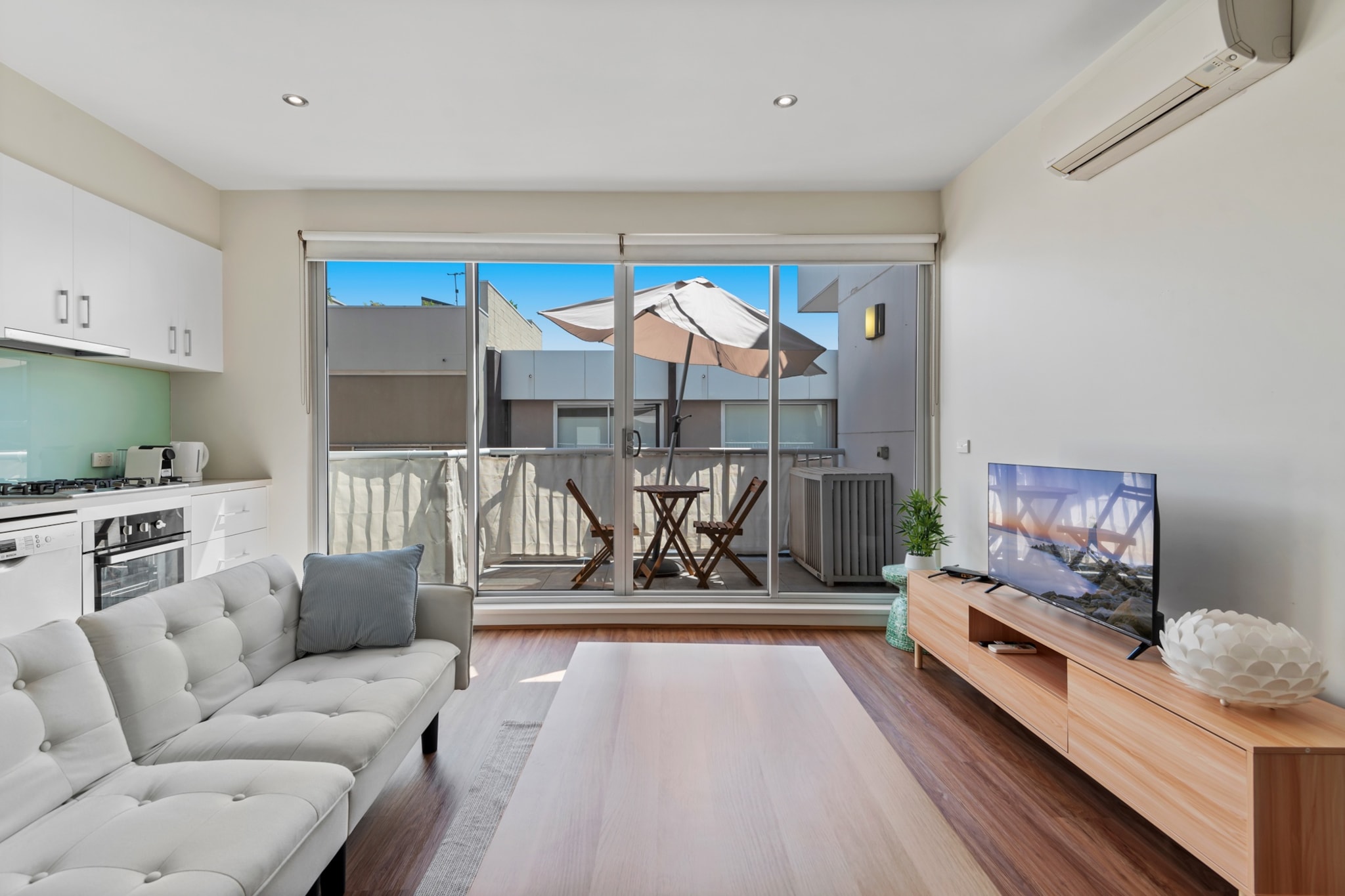 Experience stylish city living in this boutique 1-bedroom apartment in North Melbourne. Perfect for couples or solo travellers, it features a queen bed, an inviting living area, and private balcony. Enjoy a fully equipped kitchen, one bathroom, in-unit laundry, and Wi-Fi. Located near shops, public transport, and Melbourne’s CBD, it offers both convenience and comfort. With self-check-in available, this urban retreat is ideal for both short and long stays.
The space
This modern 1-bedroom 1-bath apartment blends style with practicality, creating a comfortable urban sanctuary. The open-plan living area features a two-seater couch, a TV with free-to-air channels and streaming apps, and large windows that fill the space with natural light. The adjoining kitchen is fully equipped with utensils, a gas stovetop, and an electric oven. The dining area has seating for two, while a private balcony provides outdoor seating to enjoy fresh air and city views. The bedroom offers a cosy queen-sized bed with blackout blinds for restful sleep. Additional amenities include air conditioning in the living room, a fan in the bedroom, and high-speed Wi-Fi. With its stylish décor and convenient location near public transport and local shops, this apartment is perfect for exploring Melbourne while enjoying a cosy and well-appointed home base.
Living Room
-Couch seats 2 people
-TV with free-to-air channels and streaming options (guests to use their own credentials)
Kitchen & Dining Area
-Fully equipped with cutlery and utensils
-Oven and gas stovetop
-Dining area seats 2
Bathroom & Laundry
-Laundry room available with washer and dryer
-Travel essentials, towels, and hairdryer provided
Amenity Notes
-Street parking on Leveson Street (2-hour limit)
-Air conditioning in the living room, fan in the bedroom
-Wi-Fi is available
-Private balcony with outdoor furniture
Local area description
North Melbourne is a vibrant inner-city suburb known for its heritage streets, trendy cafés, and proximity to Melbourne’s CBD. Stroll to Auction Rooms Café for award-winning coffee, grab brunch at Fandango, or Hot Poppy cafe and have a drink and dinner at the Town hall Pub. You'll easily be able to explore the vibrant food stalls at Queen Victoria Market—all within walking distance. Enjoy the green spaces of Royal Park, visit the Melbourne Zoo, or take a scenic stroll along the Capital City Trail. With trams at your doorstep, Melbourne CBD is just minutes away—perfect for work, sightseeing, or shopping!
House rules
You are staying in a friendly and peaceful neighbourhood and we kindly ask you to respect the community and your surrounding neighbours. The following strict House Rules apply:
- No loud noise between 10 pm and 8 am
- No parties or antisocial behaviour
- No additional people are to access the property without our prior approval
- No pets are allowed in the property without approval
- No smoking is allowed at any times
- If you break something, please let us know
- To help protect all floor coverings, do not wear any shoes inside the property
Please be aware that excessive noise such as amplified music, vocals or screaming or anti-social behaviour in the property or common areas can cause neighbours to complain to us, the Building Manager, Council Rangers or Police.
IMPORTANT:
- Any breach of the House Rules may lead to a $500 fine plus compensation for any cost/damage created and immediate eviction of the property without refund.
- Pets are available on request unless the property states it is pet friendly. Any stays with pets will incur an additional cleaning fee of $200.
Finally, when checking out, we kindly ask you for the following:
- Please leave all beds unmade
- Please clean up your dishes and put them away
- In case you have rearranged furniture, please put it back to the original location
- Please take out the rubbish and remember to use the right bins
- Please ensure all appliances, A/C and lights are off and doors and windows are closed.
- Please check your accommodation thoroughly before departing to avoid any unintentional items left behind.
We are not liable for any items left behind after your stay. In the rare event that a guest reports a missing item, we will make every effort to locate it for you, but we cannot guarantee its retrieval. If the item is found, we will gladly assist in arranging its return to an address within Australia, subject to postage and service fees.
Interaction with guests
Welcome to MadeComfy! Our local team curates stays in exceptional Australian & New Zealand properties, ensuring style, comfort, and prime locations for discerning guests. We prioritise your needs to provide a memorable home-away-from-home experience. Explore our digital guidebooks for local recommendations, and don't hesitate to contact us throughout your stay. We're here to ensure your comfort - enjoy your stay with MadeComfy.
Notes
- For your comfort, this property is prepared with professional-grade hotel-style linen, including a three-sheet setup, ensuring a fresh and hygienic sleep experience.
-Stairs are required inside the property
Extra Services:
- Early Check-in: Our standard check-in is at 3 pm. To guarantee early access to the property we suggest booking the night before if available. Otherwise, early check-in is subject to availability from the night before at an additional cost.
- Late check-out: Our standard check-out is at 10 am. To guarantee a later check-out of the property we suggest booking an additional night if available. Otherwise, a late check-out is subject to availability from the night before to an additional cost.
- Baggage: For security reasons, we are unable to receive or to keep unattended baggage before check-in or after check-out
- We provide a small welcome amenity pack to get your stay started.
- This booking is protected with coverage for lost baggage and emergency medical expenses, provided by Travel Support with claim upto 500 AUD (T&C Applies). For more details reach out to Guest Support team post booking.
Access description
The key collection is located offsite. Further details will be provided 3 days before check-in if your booking is successfully reserved.
Getting around
Public Transport
Nearby tram stops offer routes to Melbourne CBD, Docklands, and Brunswick. The closest train station, North Melbourne Station, connects to the city and outer suburbs.
Getting There
Melbourne Airport is approximately a 20-minute drive from the property. The Melbourne CBD is just a 10-minute drive or short tram ride away.