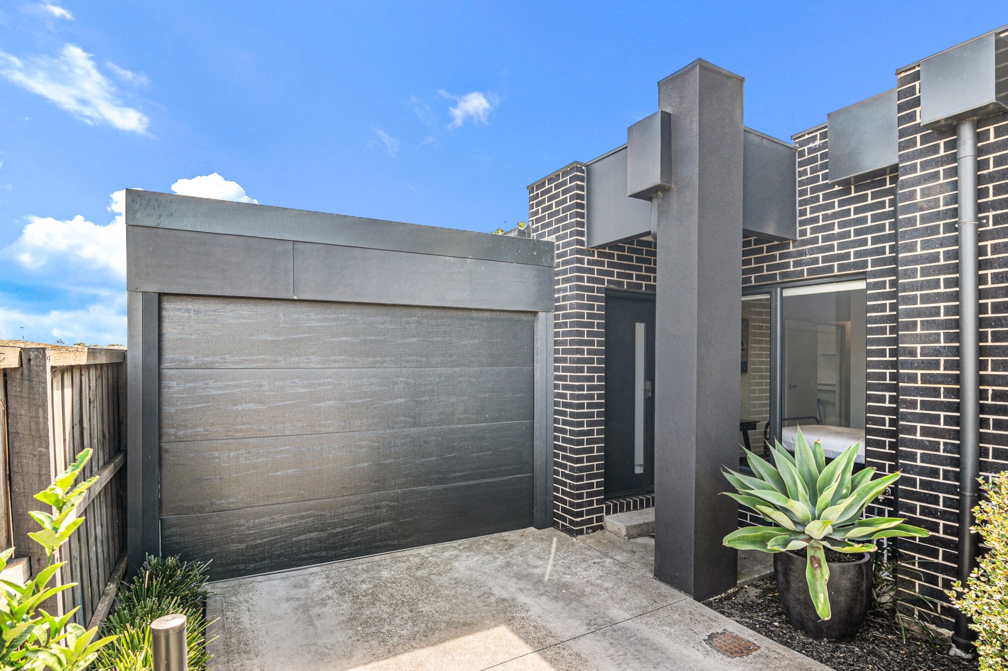 Unwind in this spacious 2-bedroom house, featuring a private garage, air conditioning, and a cosy outdoor area. Ideal for couples, solo travellers, or small groups, this stylish retreat offers a well-equipped kitchen, comfortable living space, and easy access to Glenroyâ€™s shops and transport. With Wi-Fi and self-check-in, enjoy a seamless stay in this inviting home.

The space
Welcome to your bright, modern and stylish retreat, designed for the perfect short stay for business travellers, couples, or small families. Step inside to a light-filled open-plan living space, where you can relax on the couch and enjoy your favourite shows on the TV. The fully equipped kitchen has everything you need. Dine together at the dining table or grab a coffee at the countertop. The home features two cosy bedrooms one with a queen bed and the other with a king-single bed, ensuring a restful nightâ€™s sleep. Step outside through the sliding doors to a private backyard, complete with outdoor seating for morning coffee or evening relaxation. Additional comforts include a private laundry, and ducted air conditioning, keeping you comfortable year-round. Conveniently located in Glenroy, this home provides easy access to local cafes, shops, and public transport, making it the perfect base for your stay. Whether youâ€™re here for work or leisure, this inviting and low-maintenance home is ready to welcome you!
 
Living Room
-Couch seats 6 people
-TV with Free-to-Air channels (guests to use their own credentials)
 
Kitchen & Dining Area
-Fully equipped with cutlery and utensils
-Oven and gas stovetop
-Dining area seats 6 and countertop seats 2
 
Bathroom & Laundry
-Laundry room available with washer and dryer
-Travel essentials, towels, and hairdryer provided
 
Amenity Notes
-Onsite carport parking (1 spot) + street parking
-Ducted A/C (heating + cooling) in both bedrooms and living area
-Private outdoor area with full outdoor furniture
-High-speed Wi-Fi is available
-Study nook available in the second bedroom
Local area description
Glenroy is a lively suburb in Melbourneâ€™s north, blending urban convenience with green spaces. It offers easy access to local cafÃ©s, shops, and transport links. Visit the Northern Golf Club for a round of golf, explore the scenic Moonee Ponds Creek Trail, or shop at nearby Westfield Airport West. With excellent transport options, Glenroy is a great base for exploring Melbourne.
House rules
You are staying in a friendly and peaceful neighbourhood and we kindly ask you to respect the community and your surrounding neighbours. The following strict House Rules apply:
 
- No loud noise between 10 pm and 8 am
- No parties or antisocial behaviour
- No additional people are to access the property without our prior approval
- No pets are allowed in the property without approval
- No smoking is allowed at any times
- If you break something, please let us know
- To help protect all floor coverings, do not wear any shoes inside the property
 
Please be aware that excessive noise such as amplified music, vocals or screaming or anti-social behaviour in the property or common areas can cause neighbours to complain to us, the Building Manager, Council Rangers or Police.
 
IMPORTANT:
- Any breach of the House Rules may lead to a $500 fine plus compensation for any cost/damage created and immediate eviction of the property without refund.
- Pets are available on request unless the property states it is pet friendly. Any stays with pets will incur an additional cleaning fee of $200.
 
Finally, when checking out, we kindly ask you for the following:
 
- Please leave all beds unmade
- Please clean up your dishes and put them away
- In case you have rearranged furniture, please put it back to the original location
- Please take out the rubbish and remember to use the right bins
- Please ensure all appliances, A/C and lights are off and doors and windows are closed.
- Please check your accommodation thoroughly before departing to avoid any unintentional items left behind.
 
We are not liable for any items left behind after your stay. In the rare event that a guest reports a missing item, we will make every effort to locate it for you, but we cannot guarantee its retrieval. If the item is found, we will gladly assist in arranging its return to an address within Australia, subject to postage and service fees.
Interaction with guests
Welcome to MadeComfy! Our local team curates stays in exceptional Australian & New Zealand properties, ensuring style, comfort, and prime locations for discerning guests. We prioritise your needs to provide a memorable home-away-from-home experience. Explore our digital guidebooks for local recommendations, and don't hesitate to contact us throughout your stay. We're here to ensure your comfort - enjoy your stay with MadeComfy.
Notes
For your comfort, this property is prepared with professional-grade hotel-style linen, including a three-sheet setup, ensuring a fresh and hygienic sleep experience.
Please note: Parking in the driveway is not permitted. Guests must use the garage or available street parking only. This is to ensure our neighbours have clear access to their own garage. Thank you for your understanding and cooperation.
 
Extra Services:
- Early Check-in: Our standard check-in is at 3 pm. To guarantee early access to the property we suggest booking the night before if available. Otherwise, early check-in is subject to availability from the night before at an additional cost.
- Late check-out: Our standard check-out is at 10 am. To guarantee a later check-out of the property we suggest booking an additional night if available. Otherwise, a late check-out is subject to availability from the night before to an additional cost.
- Baggage: For security reasons, we are unable to receive or to keep unattended baggage before check-in or after check-out
- We provide a small welcome amenity pack to get your stay started.
- This booking is protected with coverage for lost baggage and emergency medical expenses, provided by Travel Support with claim upto 500 AUD (T&C Applies). For more details reach out to Guest Support team post booking.
Access description
Key collection is onsite. Further details will be provided 3 days before check-in if your booking is successfully reserved.
Getting around
Public Transport
Glenroy Train Station is nearby, offering quick access to Melbourne CBD. Local bus routes connect to surrounding suburbs.
 
Getting There
The property is about a 15-minute drive from Melbourne Airport and a 30-minute train ride to Melbourne CBD.