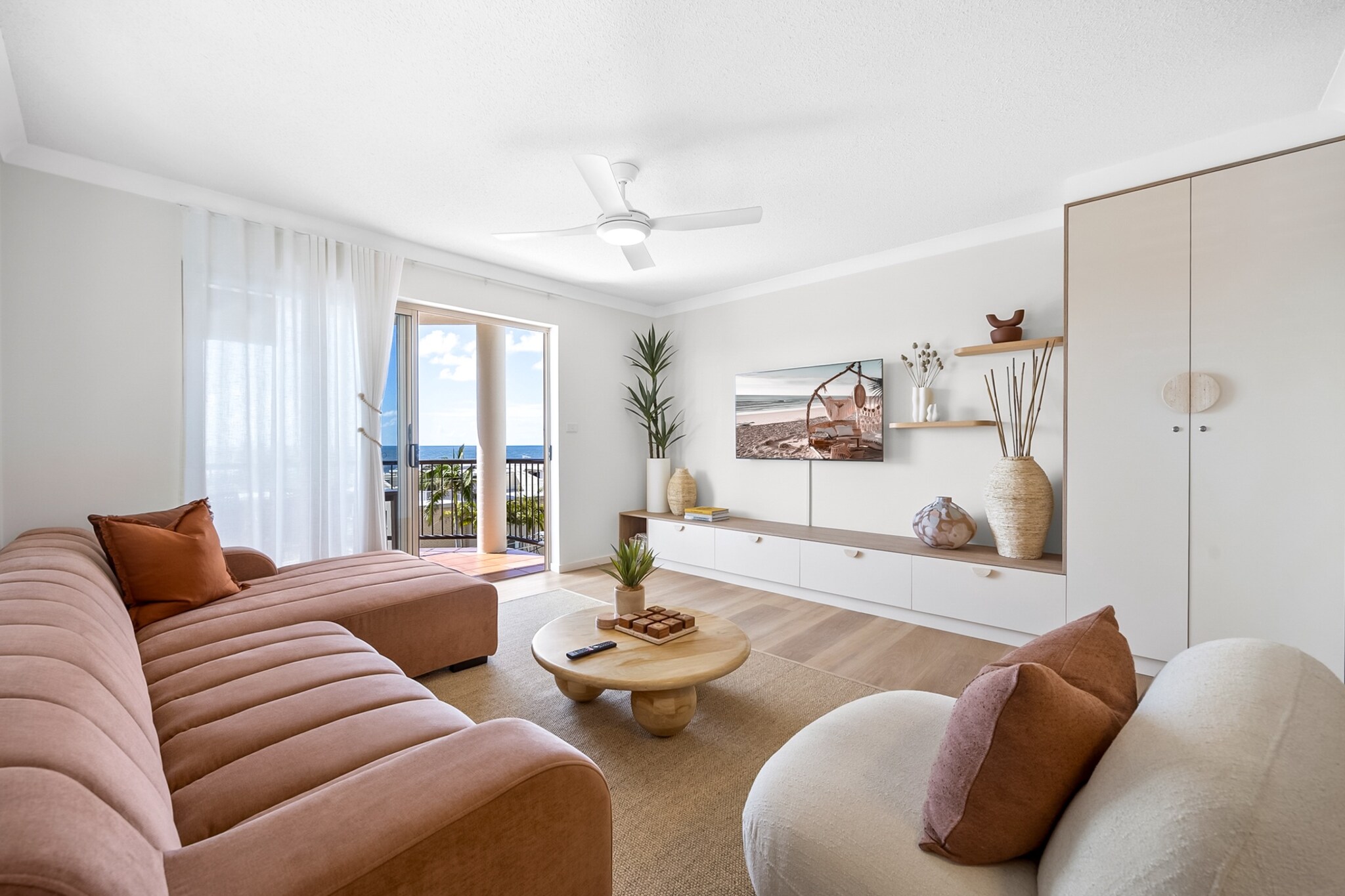This stylish apartment is just a 2-minute stroll from Kings Beach. It boasts bright, modern interiors and stunning ocean views. Ideal for families or small groups, it features a fully equipped kitchen, spacious living area, private balcony and a pool in the complex. It also features a private rooftop deck perfect for dusk alfresco dining. Enjoy easy access to restaurants, cafes, a patrolled beach, and the Kings Beach Ocean Pool and Surf Club.
The space
This stylish 2-bedroom, 2-bathroom apartment is designed for comfort and relaxation. The living area features contemporary furnishings, including a large couch and a flat-screen TV, perfect for unwinding after a day at the beach. The kitchen is fully equipped with modern appliances, including an oven, stovetop, and fridge. The two bedrooms—one with a queen bed and the other with two singles—offer a restful retreat, complete with blackout blinds for a good night's sleep. The private balcony is an ideal place to enjoy the ocean view, along with a private rooftop deck that offers stunning vistas.
 
Living Room
-Couch seats 4 people plus armchair for 1  
-TV with free-to-air and streaming (guests to use their own credentials)
-Study nook with power points
 
Kitchen & Dining Area
-Fully equipped with cutlery and utensils
-Oven and induction stovetop
-Countertop seats 4
 
Bathroom & Laundry
-Laundry room available with washer and dryer combo
-Travel essentials, towels, and hairdryer provided
 
Amenity Notes
-Onsite parking (single car garage, tight turning radius, up to a small SUV only) 
-Ceiling Fan in bedrooms & living room (no air conditioning)
-Private balcony with outdoor seating
-Private rooftop on the 4th floor
-Wi-Fi included
-Communal Pool with access from 7 am – 7 pm
Local area description
Kings Beach is one of the Sunshine Coast’s most vibrant and family-friendly destinations. Just steps from your door is the patrolled surf beach as well as the iconic oceanfront saltwater swimming pool. The foreshore buzzes with energy, featuring shaded playgrounds, splashpark, an outdoor gym and picnic areas, blending laid-back coastal charm with activities for all ages. You’ll find a variety of excellent beachside dining dotted along the foreshore, including the popular Kings Beach Surf Club.
 
The scenic coastal boardwalk links Kings Beach to nearby Happy Valley and Bulcock Beach, where calm waters are perfect for paddleboarding, kayaking, or a relaxed swim. You’ll find waterfront restaurants and cafés dotted along the way. Head north along the boardwalk for a more energising walk around the headland to Shelly Beach and Moffat Beach—both local favourites for their laid-back charm and coastal beauty.
 
With weekend markets, live music, and community events regularly enlivening the area, Kings Beach provides a vibrant and authentic Sunshine Coast experience.
House rules
You are staying in a friendly and peaceful neighbourhood and we kindly ask you to respect the community and your surrounding neighbours. The following strict House Rules apply:
 
- No loud noise between 10 pm and 8 am
- No parties or antisocial behaviour
- No additional people are to access the property without our prior approval
- No smoking is allowed at any times
- If you break something, please let us know
- To help protect all floor coverings, do not wear any shoes inside the property
 
Please be aware that excessive noise such as amplified music, vocals or screaming or anti-social behaviour in the property or common areas can cause neighbours to complain to us, the Building Manager, Council Rangers or Police.
 
IMPORTANT:
- Any breach of the House Rules may lead to a $500 fine plus compensation for any cost/damage created and immediate eviction of the property without refund.
 
 
Finally, when checking out, we kindly ask you for the following:
 
- Please leave all beds unmade
- Please clean up your dishes and put them away
- In case you have rearranged furniture, please put it back to the original location
- Please take out the rubbish and remember to use the right bins
- Please ensure all appliances, A/C and lights are off and doors and windows are closed.
- Please check your accommodation thoroughly before departing to avoid any unintentional items left behind.
 
We are not liable for any items left behind after your stay. In the rare event that a guest reports a missing item, we will make every effort to locate it for you, but we cannot guarantee its retrieval. If the item is found, we will gladly assist in arranging its return to an address within Australia, subject to postage and service fees.
Interaction with guests
Welcome to MadeComfy! Our local team curates stays in exceptional Australian & New Zealand properties, ensuring style, comfort, and prime locations for discerning guests. We prioritise your needs to provide a memorable home-away-from-home experience. Explore our digital guidebooks for local recommendations, and don't hesitate to contact us throughout your stay. We're here to ensure your comfort - enjoy your stay with MadeComfy.
Notes
- Please note, this apartment is on the third floor of the complex with stair access only (no lift).The private rooftop deck is above the apartment on the 4th floor.  
- No pets are allowed
 
For your comfort, this property is prepared with professional-grade hotel-style linen, including a three-sheet setup, ensuring a fresh and hygienic sleep experience.
 
Extra Services:
- Early Check-in: Our standard check-in is at 3 pm. To guarantee early access to the property we suggest booking the night before if available. Otherwise, early check-in is subject to availability from the night before at an additional cost.
- Late check-out: Our standard check-out is at 10 am. To guarantee a later check-out of the property we suggest booking an additional night if available. Otherwise, a late check-out is subject to availability from the night before to an additional cost.
- Baggage: For security reasons, we are unable to receive or to keep unattended baggage before check-in or after check-out
- We provide a small welcome amenity pack to get your stay started.
- This booking is protected with coverage for lost baggage and emergency medical expenses, provided by Travel Support with claim upto 500 AUD (T&C Applies). For more details reach out to Guest Support team post booking.
Access description
Key collection is onsite. Further details will be provided 3 days before check-in if your booking is successfully reserved.
Getting around
Public Transport: Bus stops are conveniently located, with services connecting to surrounding areas including Mooloolaba, Maroochydore, and beyond.
 
 
Getting There: The property is approximately 30 minutes from Sunshine Coast Airport by car, and a 1.5-hour drive from Brisbane’s CBD.