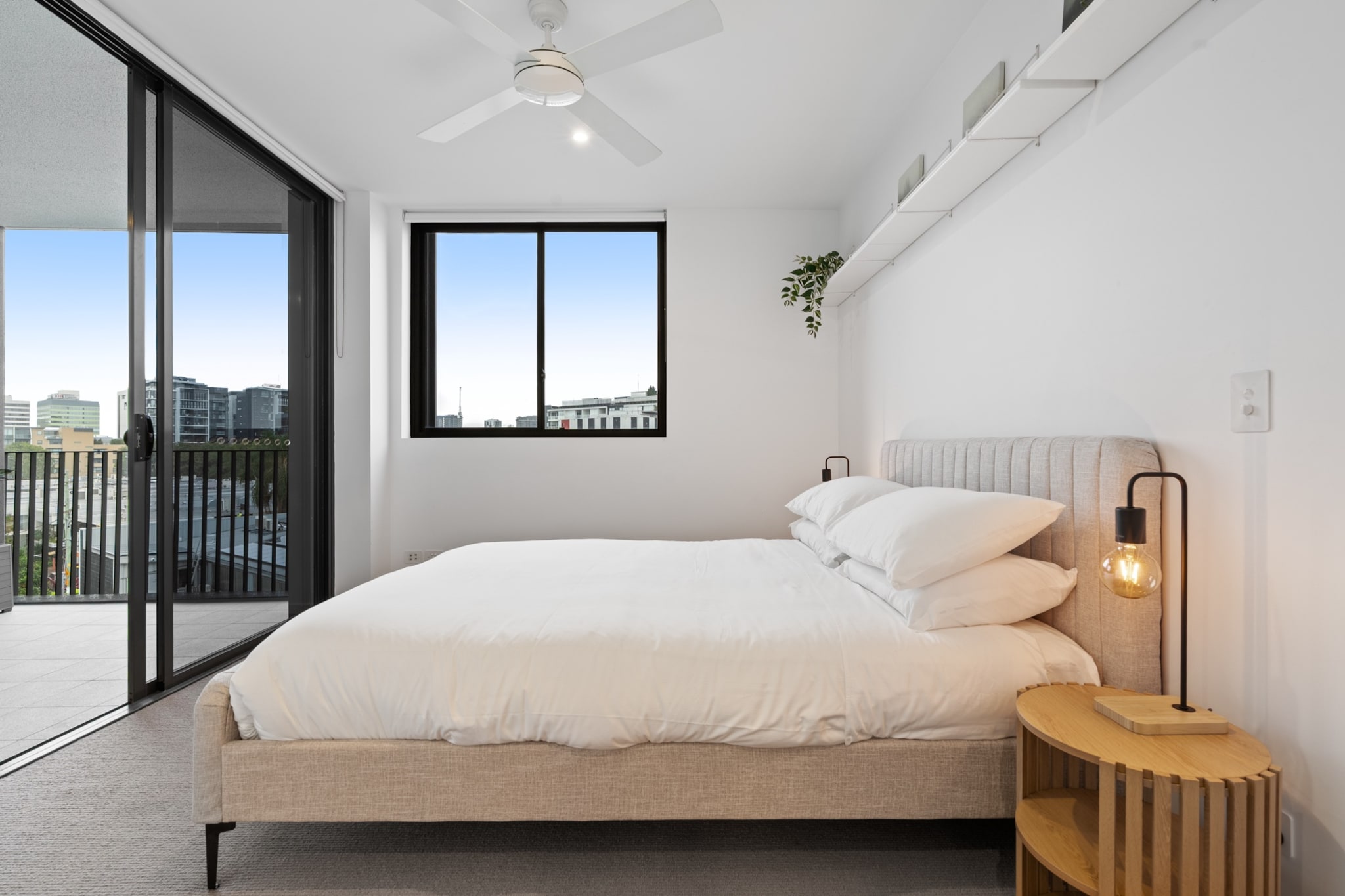 This bright, modern 1-bedroom apartment offers a comfortable retreat in the heart of West End. Ideal for both business and leisure travellers, itâ€™s within easy reach of shops, cafes, and public transport. The apartment features a fully equipped kitchen, a spacious living area, and a private balcony with seating. Enjoy the convenience of onsite parking, high-speed Wi-Fi, and air conditioning throughout. Perfect for your next stay in Brisbaneâ€™s vibrant West End.
The space
This inviting 1-bedroom, 1-bathroom apartment is designed with comfort and convenience in mind. The open-plan layout seamlessly blends the living and dining areas, with modern finishes throughout. The living room is spacious and filled with natural light, complete with a comfy couch and a TV for relaxation. Step outside to your private balcony, ideal for enjoying your morning coffee or evening wind-down.
 
The bedroom features a queen bed (with balcony access), blackout blinds for a restful nightâ€™s sleep, and ducted air conditioning to keep you comfortable throughout the year. The fully equipped kitchen offers everything you need for cooking, while the bathroom includes modern fixtures and a large shower for ultimate relaxation. Whether you're staying for a short break or a longer stay, the apartment is designed to make you feel right at home.
 
Living Room:
-Couch seats 4 people
-TV with free-to-air and streaming services (guests to use their own credentials)
 
Kitchen & Dining Area:
-Fully equipped with cookware, cutlery, and utensils
-Oven and gas stovetop
-Dining area seats 4 people
 
Bathroom & Laundry:
-Laundry room available with washer and dryer
-Travel essentials, towels and hairdryer provided
 
Amenity Notes:
-Onsite parking available with garage access (1 spot)
-Ducted A/C (heating + cooling) throughout
-Ceiling fans in the lounge & bedroom
-Dedicated study nook
-Wi-Fi is available
-Private balcony with outdoor seating for 2
-Building Amenities: Pool, Communal BBQ Area & Rooftop