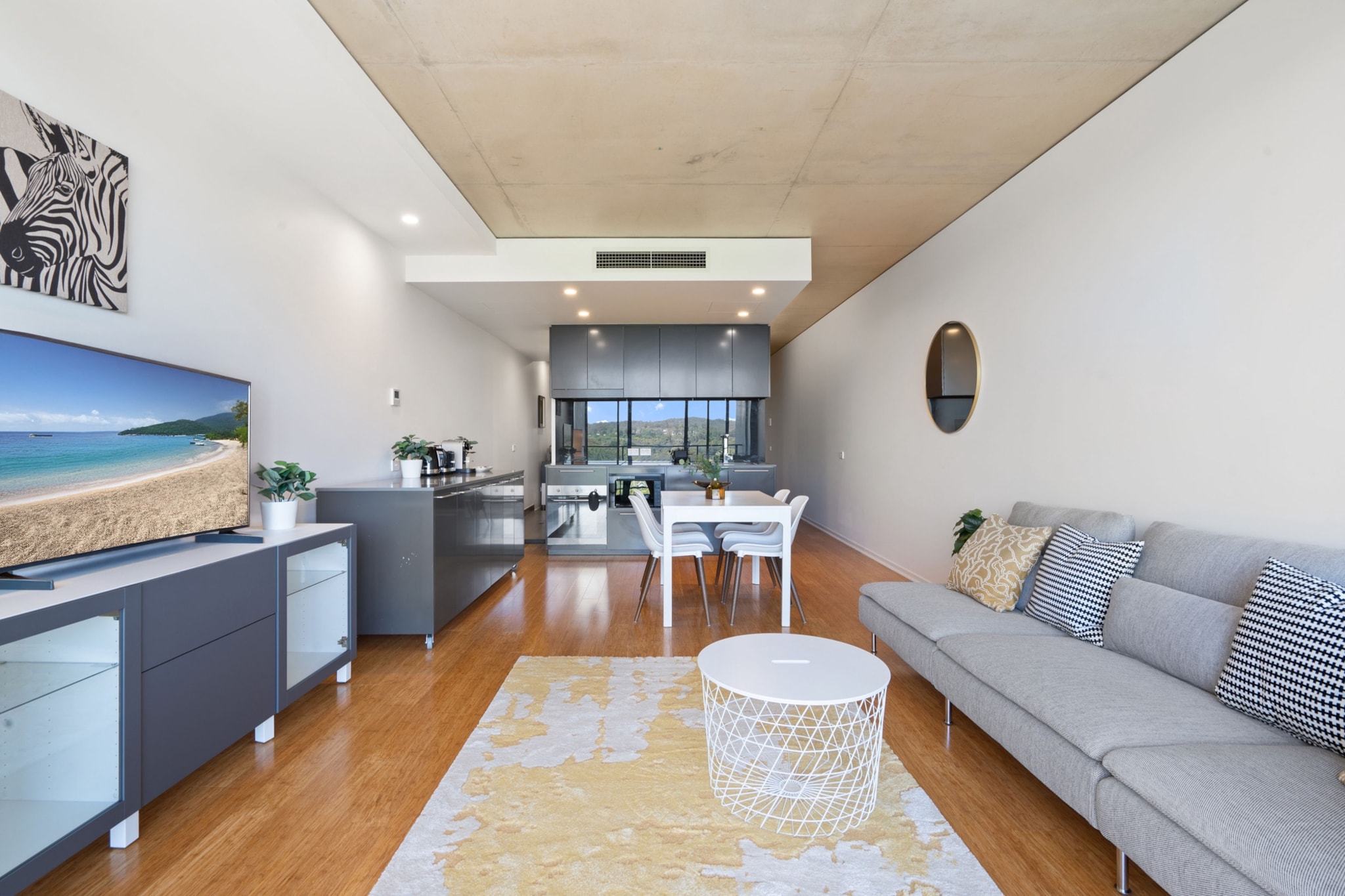 Nestled in the heart of Turner, this stylish 1-bed apartment offers effortless access to Canberraâ€™s vibrant city centre. Enjoy a comfortable stay with a well-appointed living space, private balcony, and on-site parking. The light rail stop is just outside, making it easy to explore Braddonâ€™s lively dining scene and local attractions. With modern amenities, ducted air conditioning, and a rooftop pool, this apartment is perfect for business or leisure stays.
The space
Experience urban convenience in this sleek 1-bedroom apartment, designed for comfort and ease. The open-plan living area flows onto a private balcony, where you can unwind and soak in the cityscape. Inside, a plush queen bed ensures restful sleep, complemented by blackout blinds for added privacy. The stylish lounge is furnished with a 4-seater couch and a smart TV for entertainment. A fully equipped kitchen with all essentials making home-cooked meals a breeze. The elegant bathroom is stocked with fresh towels and essential toiletries. Guests also have access to a rooftop pool with an outdoor TV, offering a luxurious escape above the city. With on-site parking and direct access to the light rail, this apartment is a perfect base to explore Canberraâ€™s cultural hotspots, renowned restaurants, and lively entertainment hubs.
 
Living Room:
-Couch seats 4 people
-Smart TV (guests to use their own credentials)
 
Kitchen & Dining Area:
-Fully equipped with cutlery and utensils
-Electric oven and electric stovetop
-Dining area seats 4
 
Bathroom & Laundry:
-Laundry room available with washer and dryer
-Travel essentials, towels, and hairdryer provided
 
Amenity Notes:
-On-site underground parking (1 standard-size spot)
-Ducted A/C (heating + cooling) in lounge and bedroom
-Wi-Fi is available
-Private balcony with outdoor seating
-Rooftop pool and outdoor TV (Level 9)