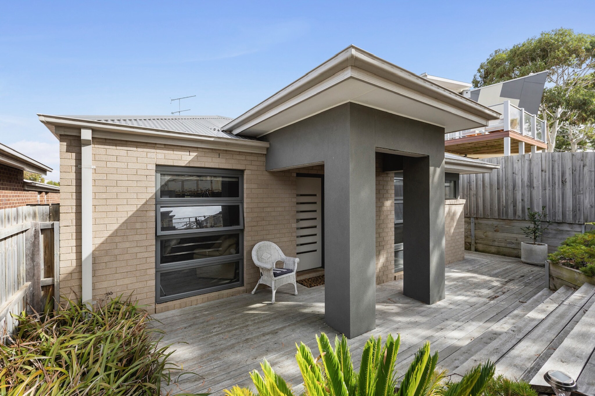 Enjoy the spacious living areas and relaxing outdoor setting at this 3-bedroom house in Torquay. Featuring a large kitchen, modern appliances, and plenty of natural light, this home is perfect for families or groups seeking comfort. The cosy outdoor area offers the ideal space to unwind, making it the perfect retreat for your next getaway. Self-check-in available for convenience.
The space
This charming house offers a welcoming blend of style and functionality. The light-filled living room features a comfortable sofa and a large TV, perfect for movie nights. The kitchen is a chef's dream with ample counter space, modern appliances, and a large fridge. Each of the 3 bedrooms provides ample space and comfort, including blackout blinds for a restful night’s sleep. The master bedroom enjoys the luxury of an en-suite bathroom. Outdoors, a cosy area awaits, ideal for enjoying the fresh air.
Living Room:
-Couch seats 6 people
-TV with streaming apps available (guests to use their own credentials)
Kitchen & Dining Area:
-Fully equipped with cutlery and utensils
-Gas stovetop with 5 burners and electric oven
-Dining area seats 6 and countertop seats 2
Bathroom & Laundry:
-Laundry room available with washer and dryer
-Travel essentials, towels and hairdryer provided
Amenity Notes:
-Parking: On-street parking on Eton Road
-Ducted heating throughout
-Pedestal fans in all bedrooms
-Wi-Fi is available
-Dedicated study nook with chair & monitor
-Outdoor area with outdoor furniture for 4
Local area description
This property is located in Torquay, a popular coastal town known for its surfing culture and scenic beaches. Enjoy easy access to nearby Torquay Beach, Bell’s Beach, and the scenic Surf Coast Walk. The town is also home to a variety of cafes, restaurants, and shops for guests to explore.