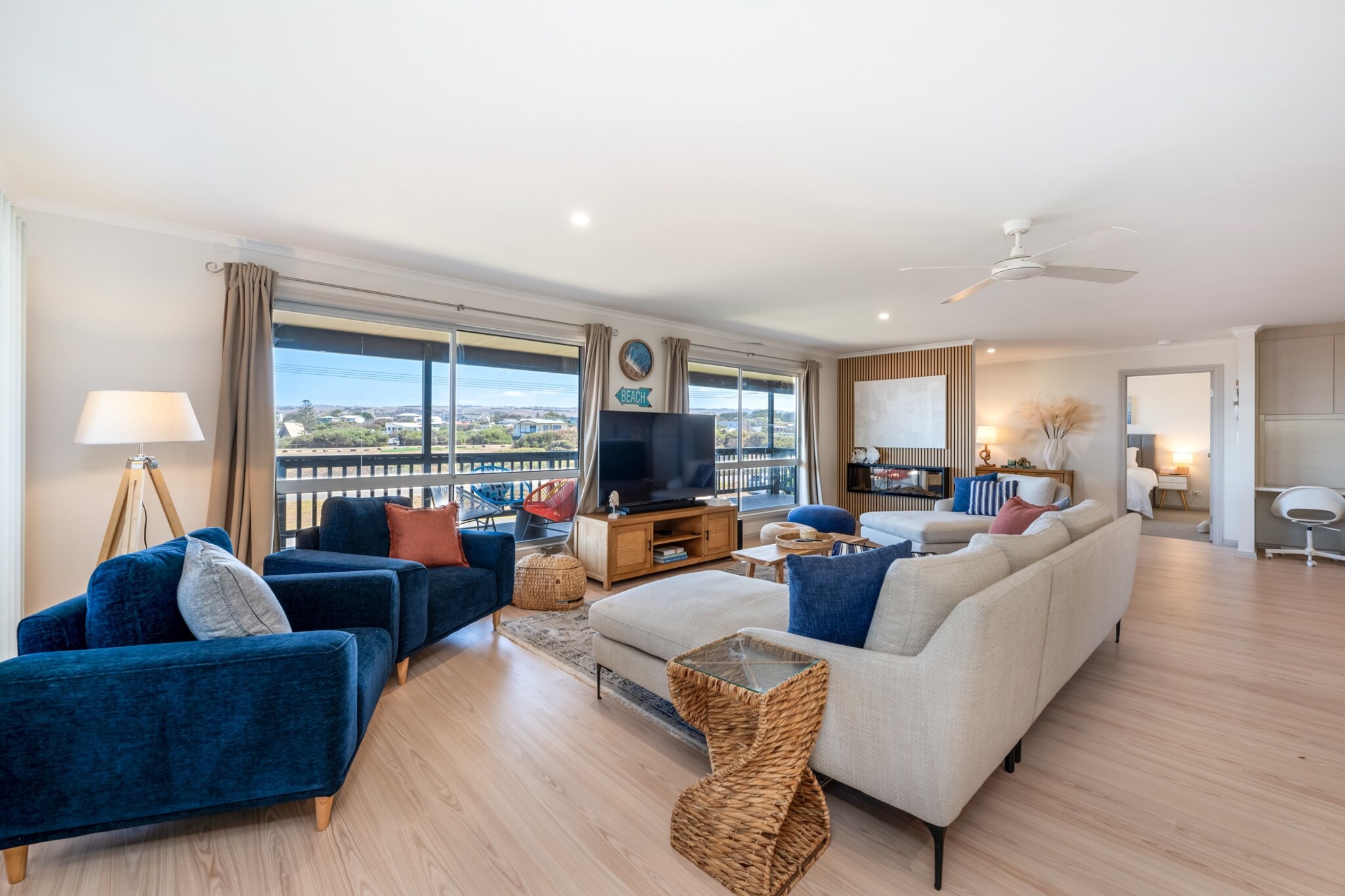 Unwind in this spacious five-bedroom coastal retreat just moments from Middleton Beach. Perfect for families and groups, the home features four queen and two single beds, a private balcony, full kitchen, and large dining area. With onsite parking, Wi-Fi, and self-check-in via lockbox, it's ideal for relaxing getaways or extended stays by the sea.
The space
This inviting upper-level home is perfect for larger groups or families seeking space and comfort by the sea. The five-bedroom layout includes four queen beds and two single beds, all equipped with blackout blinds and ample storage. Fans are available in most rooms to keep things breezy. Polished wooden floorboards run throughout, adding warmth to the open-plan living and dining area. A seven-seater couch anchors the lounge, complete with a TV. The stylish kitchen is fully equipped, including an electric oven and induction cooktop, with a spacious dining area that seats twelve and two additional countertop stools. A private balcony with full outdoor seating invites you to unwind outdoors. Guests also have access to a private laundry, an electric fireplace for ambience, and a cosy study nook beside the kitchen—perfect for remote work or reading.
Living Room
- Couch and armchairs seat up to 7 people
- TV with Free-to-Air and streaming services (guests to use their own credentials)
Kitchen & Dining Area
- Fully equipped with cutlery and utensils
- Induction stovetop and electric oven
- The dining area seats 12 and the countertop seats 2
Bathroom & Laundry
- Laundry room available with washer/dryer combo
- Travel essentials, towels and hairdryer provided
Amenity Notes
- Shared onsite parking: 1 garage space (3x6m) + 6 driveway spots
- Ceiling fans in the living area and 3 of the 5 bedrooms
- Split-type A/C (heating + cooling) in the dining area
- Study nook located at the entrance next to the kitchen
- Wi-Fi is available
- Private balcony with full outdoor furniture and BBQ
- Electric fireplace and sea views
Local area description
Middleton is a charming beachside town perfect for a laid-back coastal escape. Stroll to Middleton Beach, catch surf breaks at Goolwa, or explore the local cafés and galleries. Just minutes from Port Elliot’s heritage streets and seaside charm.
House rules
You are staying in a friendly and peaceful neighbourhood and we kindly ask you to respect the community and your surrounding neighbours. The following strict House Rules apply:
- No loud noise between 10 pm and 8 am
- No parties or antisocial behaviour
- No additional people are to access the property without our prior approval
- No pets are allowed in the property
- No smoking is allowed at any times
- If you break something, please let us know
- To help protect all floor coverings, do not wear any shoes inside the property
Please be aware that excessive noise such as amplified music, vocals or screaming or anti-social behaviour in the property or common areas can cause neighbours to complain to us, the Building Manager, Council Rangers or Police.
IMPORTANT:
- Any breach of the House Rules may lead to a $500 fine plus compensation for any cost/damage created and immediate eviction of the property without refund.
Finally, when checking out, we kindly ask you for the following:
- Please leave all beds unmade
- Please clean up your dishes and put them away
- In case you have rearranged furniture, please put it back to the original location
- Please take out the rubbish and remember to use the right bins
- Please ensure all appliances, A/C and lights are off and doors and windows are closed.
- Please check your accommodation thoroughly before departing to avoid any unintentional items left behind.
We are not liable for any items left behind after your stay. In the rare event that a guest reports a missing item, we will make every effort to locate it for you, but we cannot guarantee its retrieval. If the item is found, we will gladly assist in arranging its return to an address within Australia, subject to postage and service fees.
Interaction with guests
Welcome to MadeComfy! Our local team curates stays in exceptional Australian & New Zealand properties, ensuring style, comfort, and prime locations for discerning guests. We prioritise your needs to provide a memorable home-away-from-home experience. Explore our digital guidebooks for local recommendations, and don't hesitate to contact us throughout your stay. We're here to ensure your comfort - enjoy your stay with MadeComfy.
Notes
-Stairs inside the property
-Stairs into the property
-Please note, the downstairs area may be occupied with other guests, please be respectful.
This property is set up with home-style linen, laundered and prepared for your stay to provide a comfy and familiar experience.
Extra Services:
- Early Check-in: Our standard check-in is at 3 pm. To guarantee early access to the property we suggest booking the night before if available. Otherwise, early check-in is subject to availability from the night before at an additional cost.
- Late check-out: Our standard check-out is at 10 am. To guarantee a later check-out of the property we suggest booking an additional night if available. Otherwise, a late check-out is subject to availability from the night before to an additional cost.
- Baggage: For security reasons, we are unable to receive or to keep unattended baggage before check-in or after check-out
- We provide a small welcome amenity pack to get your stay started.
- This booking is protected with coverage for lost baggage and emergency medical expenses, provided by Travel Support with claim upto 500 AUD (T&C Applies). For more details reach out to Guest Support team post booking.
Access description
Key collection is onsite. Further details will be provided 3 days before check-in if your booking is successfully reserved.
Getting around
Public Transport
Middleton is serviced by local buses with connections to Goolwa and Victor Harbor.
Getting There
Approx. 1 hr 15 mins (85 km) from Adelaide Airport and 1 hr 10 mins from Adelaide CBD.