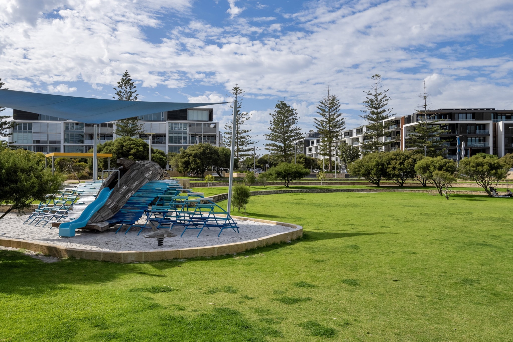This spacious 1-bedroom, 1-bathroom apartment offers modern comfort in vibrant North Fremantle. Featuring a private balcony with BBQ, ducted A/C, smart TV, and a full kitchen, it's ideal for relaxing or entertaining. Access the rooftop area and enjoy onsite parking in a prime beachside location.
Public Transport
North Fremantle Station is a short walk away, offering direct trains to Perth CBD and Fremantle. Local buses run to Cottesloe and surrounding suburbs.
Getting There
About 35 mins by car from Perth Airport and 25 mins from Perth CBD.
The space
Designed with comfort in mind, this bright, spacious apartment features wooden floors and a clean, modern aesthetic throughout. The serene bedroom includes a queen bed with bedside tables, blackout blinds, and ducted air conditioning. The open-plan living area is furnished with a three-seater sofa bed (for 1 additional adult guest or 2 childen / sofa bed is double bed size), smart TV, rug, and coffee table—perfect for lounging. A well-equipped kitchen with electric oven and induction stovetop, microwave, coffee machine, and generous bench space flows into a dining space seating four, plus a countertop with three stools. A private balcony opens from the living area and features a full outdoor setting and BBQ for easy alfresco dining. The apartment also includes a bathroom, a private laundry area with washer and dryer, and convenient lift access, as well as full access to the communal rooftop area. Ideal for extended stays or short getaways near the coast.
Living Room
-Couch seats 3 people
-TV with Free-to-Air and streaming (guests to use their own credentials)
- Sofa bed available for 1 additional adult guest or 2 children (double sofa bed)
Kitchen & Dining Area
-Fully equipped with cookware, cutlery, and utensils
-Oven and induction stovetop
-Dining area seats 4, and countertop seats 3
Bathroom & Laundry
-Laundry room available with washer/dryer combo
-Travel essentials, towels and hairdryer provided
Amenity Notes
-The communal rooftop pool
-Onsite car bay for 1 vehicle (max height 2.2m)
-Air conditioning and heating in the lounge room and bedroom
-Wi-Fi is available
-Private balcony with BBQ and outdoor furniture
-Rooftop area, BBQ, and lounge area on level 5
-Yoga studio available on ground level (additional cost, independently operated)