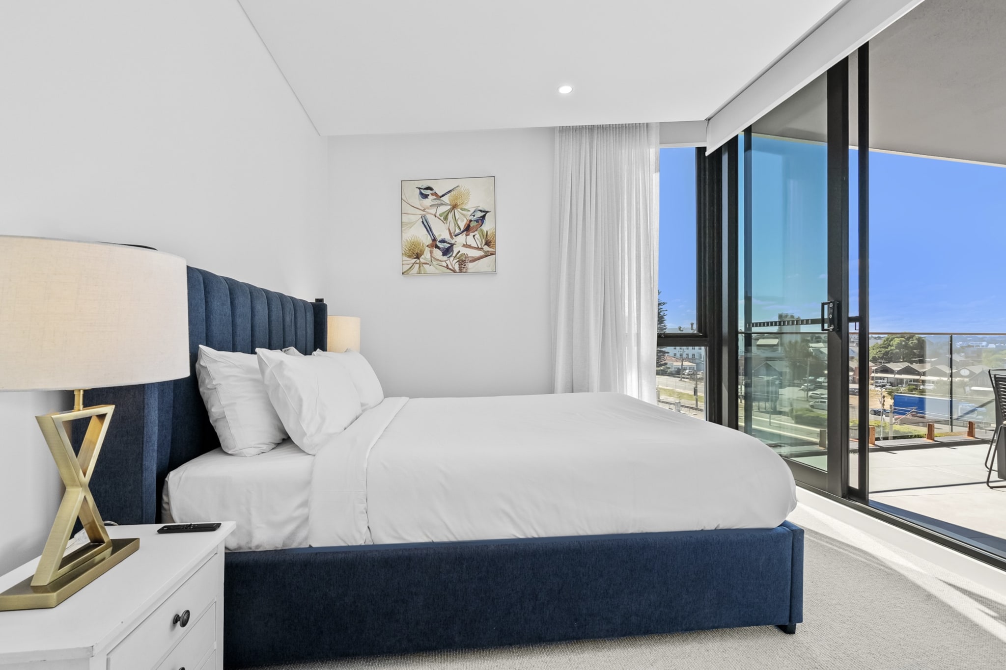 This modern 2-bedroom apartment in North Fremantle features a spacious living area and a private balcony. Enjoy access to building amenities, including a rooftop on Level 5, perfect for relaxation. The apartment is fully equipped for a comfortable stay, with a well-stocked kitchen and air conditioning. Ideal for small families or groups looking to explore Fremantle.
The space
Step into this stunning third-floor oceanview apartment, where contemporary elegance meets serene coastal charm. With expansive views of the sparkling ocean, this property offers a peaceful and luxurious retreat, perfect for those seeking both comfort and style. The open-plan living space features tasteful decor, with soft, neutral tones complemented by high-end finishes. Floor-to-ceiling windows allow natural light to flood the space, enhancing the airy atmosphere and offering breathtaking views of the water. The fully equipped kitchen is a dream for culinary enthusiasts, boasting sleek countertops, premium appliances, and ample space for preparing meals. The living area is equally inviting, offering plush seating and a smart TV, creating the ideal setting to relax after a day of exploring the surrounding area. The master bedroom is a true sanctuary, featuring a king-sized bed and balcony access. The second bedroom, equally luxurious, offers a comfortable bed and ample storage space. Both bedrooms have a wall-mounted TV and sliding wardrobes. With its prime position on the third floor, this apartment also features access to a private balcony where you can unwind with a glass of wine while watching the sunset paint the sky. The luxury touches and scenic vistas make this oceanview apartment a truly exceptional escape.
Living Room
-Couch seats 3 people (recliners) + armchair
-TV with Free-to-Air and streaming (guests to use their own credentials)
Kitchen & Dining Area
-Fully equipped with cookware, cutlery, and utensils
-Oven and induction stovetop
-Dining area seats 4
Bathroom & Laundry
-Laundry room available with washer/dryer combo
-Travel essentials, towels and hairdryer provided
Amenity Notes
-Onsite car bay for 1 vehicle (max height 2.2m)
-Air conditioning and heating in the lounge room and bedrooms
-Wi-Fi is available
-Study nook at the entrance
-Private balcony with outdoor furniture and ocean views
-Communal rooftop BBQ, and lounge area on level 5.
-Yoga studio available on ground level (additional cost, independently operated)
House rules
You are staying in a friendly and peaceful neighbourhood and we kindly ask you to respect the community and your surrounding neighbours. The following strict House Rules apply:
- No loud noise between 10 pm and 8 am
- No parties or antisocial behaviour
- No additional people are to access the property without our prior approval
- No pets are allowed in the property without approval
- No smoking is allowed at any times
- If you break something, please let us know
- To help protect all floor coverings, do not wear any shoes inside the property
Please be aware that excessive noise such as amplified music, vocals or screaming or anti-social behaviour in the property or common areas can cause neighbours to complain to us, the Building Manager, Council Rangers or Police.
IMPORTANT:
- Any breach of the House Rules may lead to a $500 fine plus compensation for any cost/damage created and immediate eviction of the property without refund.
- Pets are available on request unless the property states it is pet friendly. Any stays with pets will incur an additional cleaning fee of $200.
Finally, when checking out, we kindly ask you for the following:
- Please leave all beds unmade
- Please clean up your dishes and put them away
- In case you have rearranged furniture, please put it back to the original location
- Please take out the rubbish and remember to use the right bins
- Please ensure all appliances, A/C and lights are off and doors and windows are closed.
- Please check your accommodation thoroughly before departing to avoid any unintentional items left behind.
We are not liable for any items left behind after your stay. In the rare event that a guest reports a missing item, we will make every effort to locate it for you, but we cannot guarantee its retrieval. If the item is found, we will gladly assist in arranging its return to an address within Australia, subject to postage and service fees.
Interaction with guests
Welcome to MadeComfy! Our local team curates stays in exceptional Australian & New Zealand properties, ensuring style, comfort, and prime locations for discerning guests. We prioritise your needs to provide a memorable home-away-from-home experience. Explore our digital guidebooks for local recommendations, and don't hesitate to contact us throughout your stay. We're here to ensure your comfort - enjoy your stay with MadeComfy.
Notes
For your comfort, this property is prepared with professional-grade hotel-style linen, including a three-sheet setup, ensuring a fresh and hygienic sleep experience.
The communal rooftop pool is currently unavailable until August 2025
Extra Services:
- Early Check-in: Our standard check-in is at 3 pm. To guarantee early access to the property we suggest booking the night before if available. Otherwise, early check-in is subject to availability from the night before at an additional cost.
- Late check-out: Our standard check-out is at 10 am. To guarantee a later check-out of the property we suggest booking an additional night if available. Otherwise, a late check-out is subject to availability from the night before to an additional cost.
- Baggage: For security reasons, we are unable to receive or to keep unattended baggage before check-in or after check-out
- We provide a small welcome amenity pack to get your stay started.
- Please contact MadeComfy directly if you wish to book an adjoining room.
- This booking is protected with coverage for lost baggage and emergency medical expenses, provided by Travel Support with claim upto 500 AUD (T&C Applies). For more details reach out to Guest Support team post booking.
-Communal outdoor pool
Access description
Key collection is onsite. Information will be sent 3 days before check-in if your booking is approved.
One room will be locked off with no guest access.
Getting around
Public Transport
North Fremantle Station is a short walk away, offering direct trains to Perth CBD and Fremantle. Local buses run to Cottesloe and surrounding suburbs.
Getting There
About 35 mins by car from Perth Airport and 25 mins from Perth CBD.