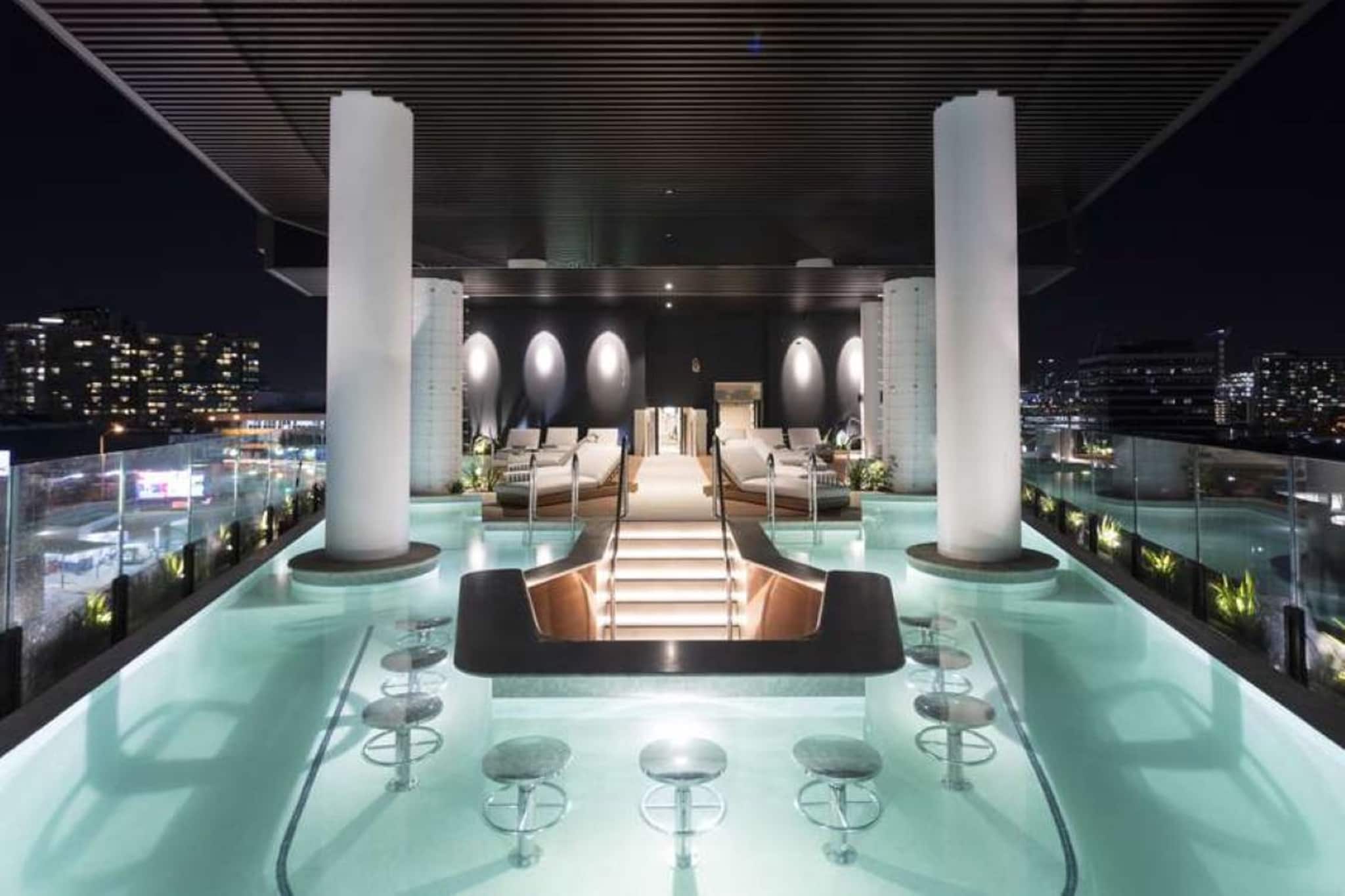 Bed Linen, Elevator, Hot Water, Internet Access DSL, Safe, Wardrobe, Living room(TV, seating area), Kitchen(dining table, stove, electric kettle, toaster, coffee machine, oven, microwave, dishwasher, fridge, freezer, dishes and cutlery, Coffee), bedroom(Queen Bed), bedroom(Queen Bed), bedroom(double bed), bathroom(bath tub, shower, washbasin, toilet, hairdryer, Towels/Sheets (Incl.), shampoo, body soap, Essentials), bathroom(shower, washbasin, toilet, hairdryer, Towels/Sheets (Incl.), shampoo, body soap, Essentials), bathroom(shower, washbasin, toilet, hairdryer, Towels/Sheets (Incl.), shampoo, body soap, Essentials), First Aid, Indoor pool, Play area, tumble dryer, washing machine, heating, air conditioning, swimming pool, private outdoor pool, iron, Carbon monoxide detector, Conditioner, Long term stays allowed, Room-darkening shades, Shower gel, Town, Wine glasses