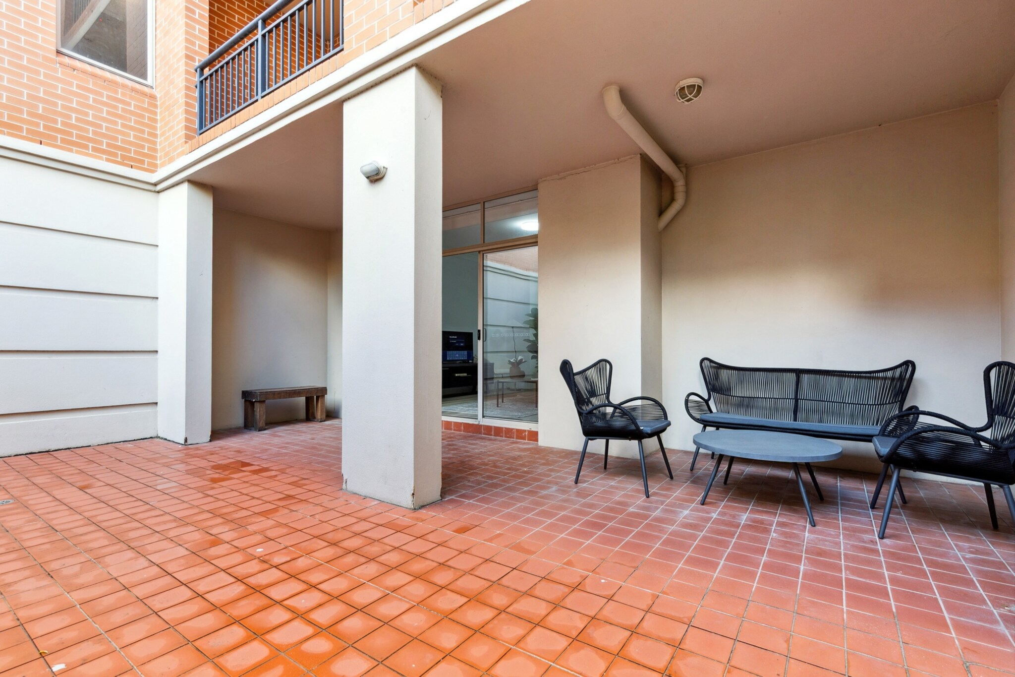 Enjoy a stylish Camperdown retreat in this spacious two-bedroom apartment. With a private courtyard, modern kitchen, and direct access to a communal pool, itâ€™s perfect for families or professionals. Secure garage parking, self-check-in, and comfortable amenities ensure a relaxing stay in Sydneyâ€™s vibrant Inner West.
The space
This elegant two-bedroom apartment offers a seamless blend of modern comfort and urban convenience. The sunlit living area features wooden flooring, a two-seater couch, and curated dÃ©cor for a homely touch. A glass door opens directly to a charming courtyard, where youâ€™ll find outdoor furniture ideal for alfresco dining or morning coffee. The master bedroom includes a king bed, an ensuite, and a balcony, while the second bedroom has a queen bed. Both feature blackout blinds and fans for year-round comfort. The sleek kitchen features electric appliances and all the essentials, seamlessly flowing into a dining area with seating for four. Two modern bathrooms, one ensuite, are thoughtfully stocked with towels and a hairdryer. A private laundry with washer and dryer adds convenience, while the secure garage and direct pool access from the courtyard complete the experience.
 
Living Room
-Couch seats 2 people
-TV with digital platforms (guests to use their own credentials)
 
Kitchen & Dining Area
-Fully equipped with cutlery and utensils
-Oven and electric stovetop
-Dining area seats 4
 
Bathroom & Laundry
-Laundry room available with washer and dryer
-Travel essentials, towels and hairdryer provided
 
Amenity Notes
-Onsite garage parking for 1 car (access via Briggs St)
-A/C (heating + cooling) in master bedroom and living room
-Study nook in the master bedroom
-Wi-Fi is available
-Private Amenities: Direct courtyard access with outdoor seating, balcony off master bedroom
-Building Amenities: Communal pool accessible from the courtyard
Local area description
Located in Sydneyâ€™s vibrant Inner West, Camperdown blends urban charm with green spaces and cultural flair. Steps from Royal Prince Alfred Hospital and the University of Sydney, the area is dotted with trendy cafÃ©s, bakeries, and parks. Explore nearby Newtownâ€™s famous King Street, Camperdown Park, and Carriageworks Arts Centre.
House rules
You are staying in a friendly and peaceful neighbourhood and we kindly ask you to respect the community and your surrounding neighbours. The following strict House Rules apply:
 
- No loud noise between 10 pm and 8 am
- No parties or antisocial behaviour
- No additional people are to access the property without our prior approval
- No pets are allowed in the property without approval
- No smoking is allowed at any times
- If you break something, please let us know
- To help protect all floor coverings, do not wear any shoes inside the property
 
Please be aware that excessive noise such as amplified music, vocals or screaming or anti-social behaviour in the property or common areas can cause neighbours to complain to us, the Building Manager, Council Rangers or Police.
 
IMPORTANT:
- Any breach of the House Rules may lead to a $500 fine plus compensation for any cost/damage created and immediate eviction of the property without refund.
- Pets are available on request unless the property states it is pet friendly. Any stays with pets will incur an additional cleaning fee of $200.
 
Finally, when checking out, we kindly ask you for the following:
 
- Please leave all beds unmade
- Please clean up your dishes and put them away
- In case you have rearranged furniture, please put it back to the original location
- Please take out the rubbish and remember to use the right bins
- Please ensure all appliances, A/C and lights are off and doors and windows are closed.
- Please check your accommodation thoroughly before departing to avoid any unintentional items left behind.
 
We are not liable for any items left behind after your stay. In the rare event that a guest reports a missing item, we will make every effort to locate it for you, but we cannot guarantee its retrieval. If the item is found, we will gladly assist in arranging its return to an address within Australia, subject to postage and service fees.
Interaction with guests
Welcome to MadeComfy! Our local team curates stays in exceptional Australian & New Zealand properties, ensuring style, comfort, and prime locations for discerning guests. We prioritise your needs to provide a memorable home-away-from-home experience. Explore our digital guidebooks for local recommendations, and don't hesitate to contact us throughout your stay. We're here to ensure your comfort - enjoy your stay with MadeComfy.
Notes
- For your comfort, this property is prepared with professional-grade hotel-style linen, including a three-sheet setup, ensuring a fresh and hygienic sleep experience.
- The fire alarms in this property are directly connected to the local fire brigade. If triggered, they may result in an automatic call-out. Any fees incurred due to a false alarm will be passed on to the guest for payment.
 
Extra Services:
- Early Check-in: Our standard check-in is at 3 pm. To guarantee early access to the property we suggest booking the night before if available. Otherwise, early check-in is subject to availability from the night before at an additional cost.
- Late check-out: Our standard check-out is at 10 am. To guarantee a later check-out of the property we suggest booking an additional night if available. Otherwise, a late check-out is subject to availability from the night before to an additional cost.
- Baggage: For security reasons, we are unable to receive or to keep unattended baggage before check-in or after check-out
- We provide a small welcome amenity pack to get your stay started.
- This booking is protected with coverage for lost baggage and emergency medical expenses, provided by Travel Support with claim upto 500 AUD (T&C Applies). For more details reach out to Guest Support team post booking.
Access description
Key collection is onsite. Further details will be provided 3 days before check-in if your booking is successfully reserved.
Getting around
Public Transport
Buses run frequently along Missenden Rd and Parramatta Rd. Newtown and Macdonaldtown train stations are both a short walk away.
 
Getting There
Camperdown is approx. 15 min (6 km) from Sydney CBD and 20 min (8 km) from Sydney Airport by car or rideshare.