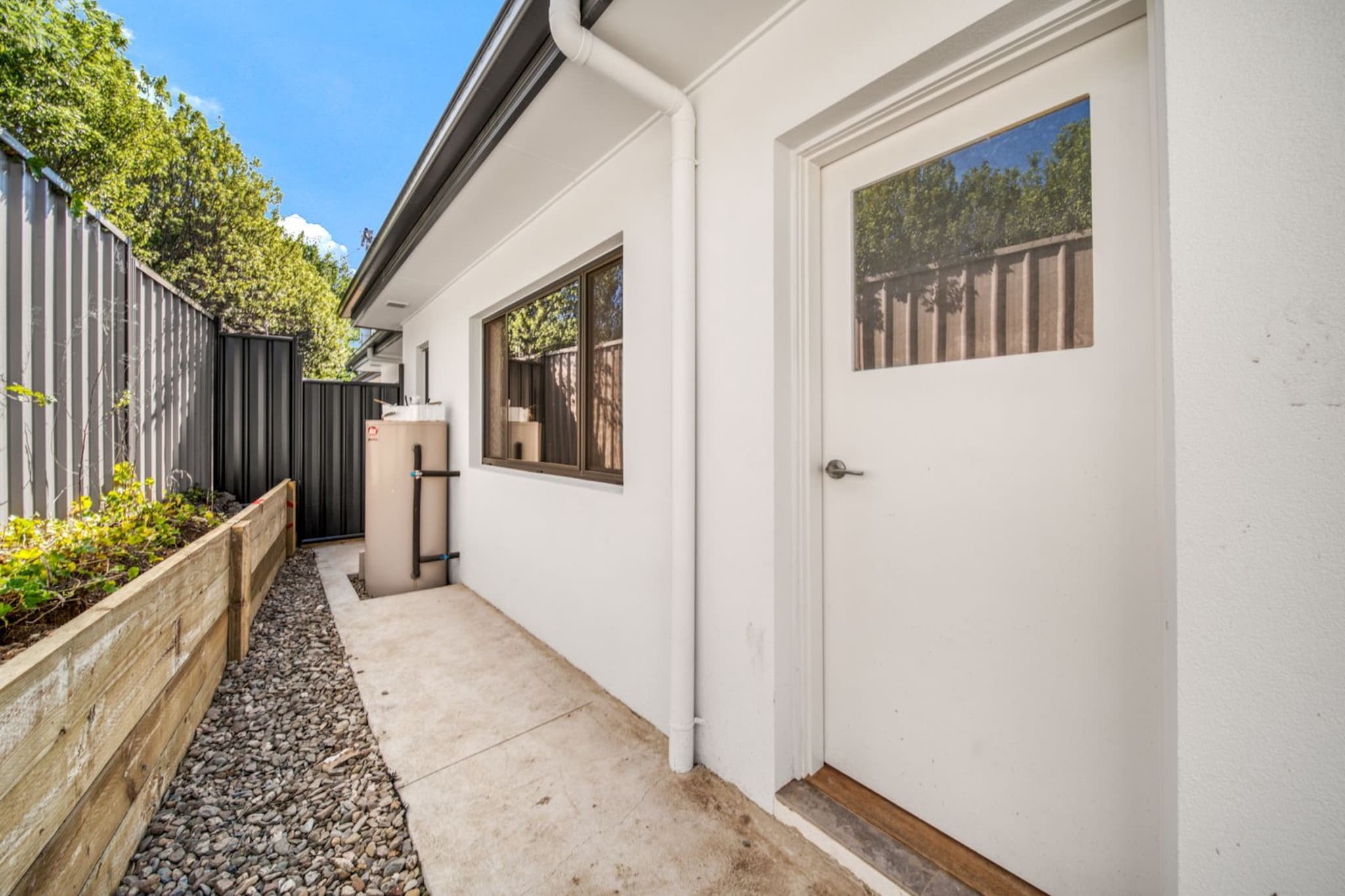 This charming attached independent flat offers a peaceful stay with a comfortable layout. Perfect for families or couples, it features a living area, a well-equipped kitchen, and a lovely outdoor area. Located in a quiet neighbourhood close to shops and parks, it provides a relaxing retreat while still being easily accessible to essential amenities. Enjoy Netflix, a fully equipped kitchen, and self-check-in for a smooth arrival.
The space
This home is a peaceful sanctuary with a well-appointed living space. The cosy living room, with a comfortable sofa set and a TV offering streaming, invites you to unwind. The kitchen is designed for practicality, featuring an induction stovetop, microwave, and a variety of kitchen essentials to make meal preparation easy. A double-sized bed with blackout blinds ensures a restful sleep, while the modern bathroom offers convenience and comfort. Outside, the private outdoor space provides a serene escape.
Living Room:
- Couch seats 3 people
- TV with Streaming (guests to use their own credentials)
Kitchen & Dining Area:
- Fully equipped with cutlery and utensils
- Microwave, coffee machine and induction stovetop
- Dining area seats 4
Bathroom & Laundry:
- Laundry area available with washer only (kitchen)
- Travel essentials, towels, and a hairdryer are provided
Amenity Notes:
- Off-street parking for 1 vehicle
- Ducted A/C throughout
- Wi-Fi is available
- Private outdoor area with seating for 2
Local area description
This home is located in the peaceful suburb of Kambah, ACT, just a short distance from local shops, parks, and family-friendly activities. Nearby, you'll find the scenic Murrumbateman Wine Region, the Kambah Pool and Recreation Centre, and the Tuggeranong Town Centre for all your shopping needs.
House rules
You are staying in a friendly and peaceful neighbourhood and we kindly ask you to respect the community and your surrounding neighbours. The following strict House Rules apply:
- No loud noise between 10 pm and 8 am
- No parties or antisocial behaviour
- No additional people are to access the property without our prior approval
- No pets are allowed in the property without approval
- No smoking is allowed at any times
- If you break something, please let us know
- To help protect all floor coverings, do not wear any shoes inside the property
Please be aware that excessive noise such as amplified music, vocals or screaming or anti-social behaviour in the property or common areas can cause neighbours to complain to us, the Building Manager, Council Rangers or Police.
IMPORTANT:
- Any breach of the House Rules may lead to a $500 fine plus compensation for any cost/damage created and immediate eviction of the property without refund.
- Pets are available on request unless the property states it is pet friendly. Any stays with pets will incur an additional cleaning fee of $200.
Finally, when checking out, we kindly ask you for the following:
- Please leave all beds unmade
- Please clean up your dishes and put them away
- In case you have rearranged furniture, please put it back to the original location
- Please take out the rubbish and remember to use the right bins
- Please ensure all appliances, A/C and lights are off and doors and windows are closed.
- Please check your accommodation thoroughly before departing to avoid any unintentional items left behind.
We are not liable for any items left behind after your stay. In the rare event that a guest reports a missing item, we will make every effort to locate it for you, but we cannot guarantee its retrieval. If the item is found, we will gladly assist in arranging its return to an address within Australia, subject to postage and service fees.
Interaction with guests
Welcome to MadeComfy! Our local team curates stays in exceptional Australian & New Zealand properties, ensuring style, comfort, and prime locations for discerning guests. We prioritise your needs to provide a memorable home-away-from-home experience. Explore our digital guidebooks for local recommendations, and don't hesitate to contact us throughout your stay. We're here to ensure your comfort - enjoy your stay with MadeComfy.
Notes
For your comfort, this property is prepared with professional-grade hotel-style linen, including a three-sheet setup, ensuring a fresh and hygienic sleep experience.
Extra Services:
- Early Check-in: Our standard check-in is at 3 pm. To guarantee early access to the property we suggest booking the night before if available. Otherwise, early check-in is subject to availability from the night before at an additional cost.
- Late check-out: Our standard check-out is at 10 am. To guarantee a later check-out of the property we suggest booking an additional night if available. Otherwise, a late check-out is subject to availability from the night before to an additional cost.
- Baggage: For security reasons, we are unable to receive or to keep unattended baggage before check-in or after check-out
- We provide a small welcome amenity pack to get your stay started.
- This booking is protected with coverage for lost baggage and emergency medical expenses, provided by Travel Support with claim upto 500 AUD (T&C Applies). For more details reach out to Guest Support team post booking.
Access description
Key collection is on-site. Further details will be provided 3 days before check-in if your booking is successfully reserved.
Please note the driveway area is shared; please be mindful and park within the sectioned area.
Also, please note that there will be residents in the main building.
Getting around
Public Transport & Getting There:
The nearest bus stop is a 10-minute walk.
The Tuggeranong train station is a 15-minute drive away.
Getting There:
The property is 25 minutes from Canberra Airport by car.
Kambah is a 20-minute drive from Canberra's city centre.