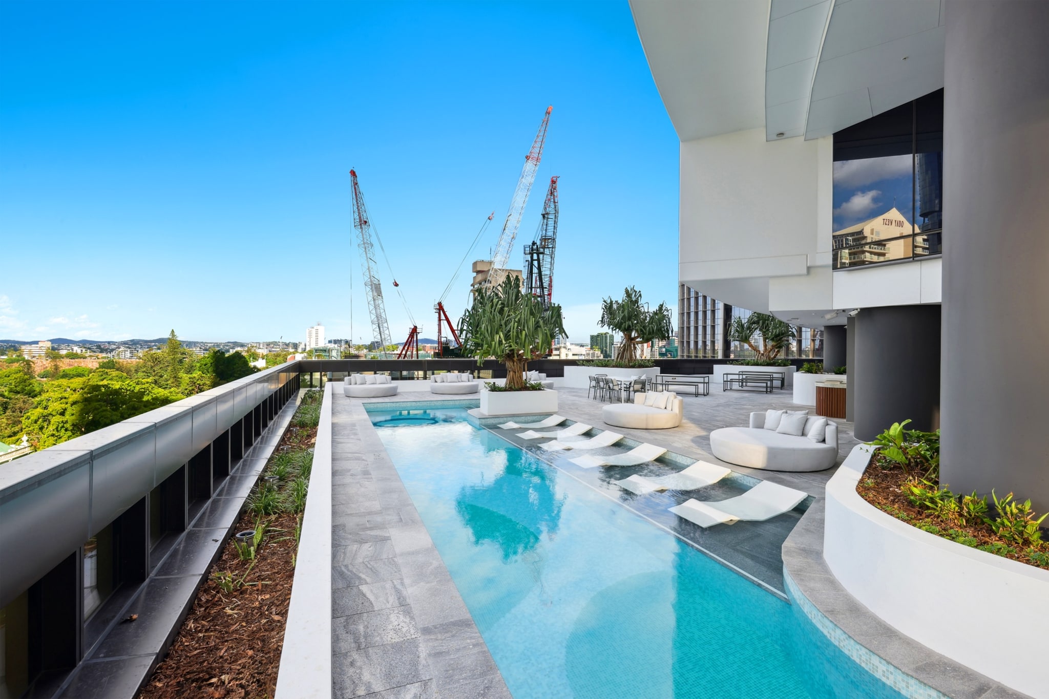 Enjoy stylish city living in this elegant 1-bed apartment in Brisbane’s heart. With ducted air-conditioning, a private balcony, and a fully equipped kitchen, this modern retreat is ideal for couples or business travellers. The building features a pool, spa, sauna, BBQ area, and residents' lounge, offering the perfect blend of comfort and convenience.
The space
Welcome to your tranquil escape in vibrant Brisbane City, perfectly positioned in the iconic arc-shaped tower of Queen’s Wharf—just moments from the Star Casino, over 50 world-class dining venues, and the scenic Brisbane River. This thoughtfully styled 1-bedroom apartment features a spacious living room with a four-seater couch, sleek coffee table, and warm floorboards, complemented by a smart TV and a cosy dining nook. The kitchen is fully equipped with all the essentials for home-style meals. The bedroom offers a queen bed, blackout blinds, ambient lighting, and ample storage, while the modern bathroom and private laundry with washer and dryer add everyday convenience. Step out to the private balcony from either the bedroom or the living area and enjoy alfresco moments with outdoor seating. Guests also have access to premium building amenities including a pool, spa, sauna, BBQ area, residents' lounge, and exclusive Sky Deck with panoramic views of Brisbane’s evolving skyline. With ducted air-conditioning and ceiling fans throughout, this apartment offers year-round comfort and style in one of the city’s most desirable locations.
Living Room
- Couch seats 4 people
- TV with streaming services (guests to use their own credentials)
Kitchen & Dining Area
- Fully equipped with cutlery and utensils
- Electric oven and gas stovetop
- Dining area seats 2
Bathroom & Laundry
- Laundry room available with washer and dryer combo
- Travel essentials, towels and hairdryer provided
Amenity Notes
- Ducted A/C (heating + cooling) throughout
- Ceiling fans in the living room and bedroom
- Wi-Fi is available
- Private balcony with outdoor seating for 2
- Building access to pool, spa, sauna, steam room, BBQ area and residents' lounge
Local area description
Located in the vibrant Brisbane City, this apartment places you near Queen Street Mall’s shops, South Bank’s cultural precinct, and the scenic Brisbane Riverwalk. Surrounded by cafés, restaurants, and public transport, enjoy the convenience of inner-city living with plenty to explore just steps away.