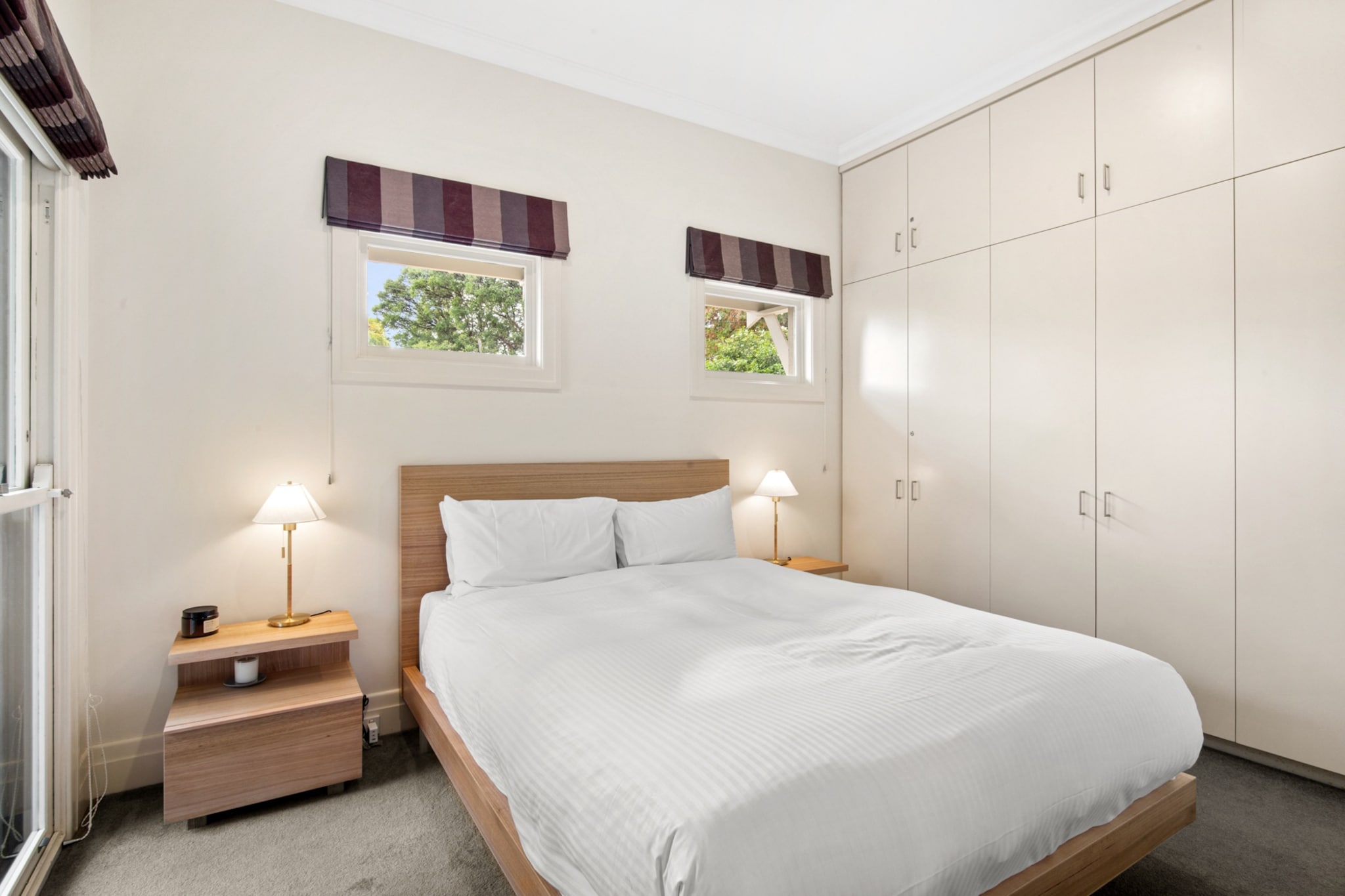 Unwind in this beautifully designed home and detached garden studio—a serene wellness escape in leafy Kew East. Tucked behind secure gates, this peaceful retreat features luxe interiors, a private outdoor sauna, and seamless access to Yarra parklands, local cafés, and city trams. Whether you're here to relax, work remotely, or spark creativity, the property offers off-street parking, modern comforts, and self-check-in for a stress-free stay.
The space
Step into a light-filled main residence where soaring ceilings, French doors, and curated finishes create a calm, elegant atmosphere. The primary home space includes a plush queen bed with premium linens, generous built-in storage, and a stylish open-plan living area. Cook with ease in the fully equipped kitchen featuring stone benchtops, gas cooktop, electric oven, and a walk-in pantry. The contemporary bathroom includes a rain shower and tranquil finishes. Just steps from the main house, a separate garden studio offers a quiet, multipurpose space—perfect for yoga, remote work, or accommodating extra guests with its Koala sofa bed. Outside, a west-facing terrace invites golden hour relaxation, while a private outdoor sauna nestled in landscaped gardens completes the wellness experience. Climate-controlled with split-system A/C, this boutique escape is just 8km from Melbourne CBD, blending mindful living with unbeatable convenience.
Main Residence:
Living Area
-Couch seats 3 people + 2 armchairs
-TV with Free-to-Air channels (guests to use their own credentials)
Kitchen & Dining Area
-Fully equipped with cutlery and utensils
-Gas stovetop, electric oven and walk-in pantry
-Outdoor dining area seats 6
Bathroom & Laundry
-Walk-in rain shower
-Laundry room available with washer and dryer
-Travel essentials, towels and hairdryer provided
Garden Studio
-Koala sofa bed (sleeps 2)
-Dedicated workspace & storage
-Portable fan and heater included
Outdoor & Amenities
-Private sauna nestled in landscaped garden
-West-facing terrace with seating, gas BBQ, and gas heater
-Firepit + outdoor seating for two
-Off-street parking in secure driveway (no size restrictions)
-Air conditioning: Split-system A/C in the main living space
-Wi-Fi is available
Local area description
Kew East offers a peaceful village feel just 8km from Melbourne’s CBD. Explore Yarra River bush trails just 500m away, relax in Hays Paddock, or browse local cafés at Harp Village. Kew Junction’s boutiques and dining options are nearby, with the Eastern Freeway offering fast city access.
House rules
You are staying in a friendly and peaceful neighbourhood and we kindly ask you to respect the community and your surrounding neighbours. The following strict House Rules apply:
- No loud noise between 10 pm and 8 am
- No parties or antisocial behaviour
- No additional people are to access the property without our prior approval
- Pets are allowed in the property with approval
- No smoking is allowed at any times
- If you break something, please let us know
- To help protect all floor coverings, do not wear any shoes inside the property
Please be aware that excessive noise such as amplified music, vocals or screaming or anti-social behaviour in the property or common areas can cause neighbours to complain to us, the Building Manager, Council Rangers or Police.
IMPORTANT:
- Any breach of the House Rules may lead to a $500 fine plus compensation for any cost/damage created and immediate eviction of the property without refund.
- Pets are available on request unless the property states it is pet friendly. Any stays with pets will incur an additional cleaning fee of $200.
Finally, when checking out, we kindly ask you for the following:
- Please leave all beds unmade
- Please clean up your dishes and put them away
- In case you have rearranged furniture, please put it back to the original location
- Please take out the rubbish and remember to use the right bins
- Please ensure all appliances, A/C and lights are off and doors and windows are closed.
- Please check your accommodation thoroughly before departing to avoid any unintentional items left behind.
We are not liable for any items left behind after your stay. In the rare event that a guest reports a missing item, we will make every effort to locate it for you, but we cannot guarantee its retrieval. If the item is found, we will gladly assist in arranging its return to an address within Australia, subject to postage and service fees.
Interaction with guests
Welcome to MadeComfy! Our local team curates stays in exceptional Australian & New Zealand properties, ensuring style, comfort, and prime locations for discerning guests. We prioritise your needs to provide a memorable home-away-from-home experience. Explore our digital guidebooks for local recommendations, and don't hesitate to contact us throughout your stay. We're here to ensure your comfort - enjoy your stay with MadeComfy.
Notes
For your comfort, this property is prepared with professional-grade hotel-style linen, including a three-sheet setup, ensuring a fresh and hygienic sleep experience.
Please note that Sauna can't be used when raining. Water can short out electrical components in the sauna heater, control panel, and lighting, potentially leading to safety hazards. Cover must be put back on after use to cover from dew and rain.
Extra Services:
- Early Check-in: Our standard check-in is at 3 pm. To guarantee early access to the property we suggest booking the night before if available. Otherwise, early check-in is subject to availability from the night before at an additional cost.
- Late check-out: Our standard check-out is at 10 am. To guarantee a later check-out of the property we suggest booking an additional night if available. Otherwise, a late check-out is subject to availability from the night before to an additional cost.
- Baggage: For security reasons, we are unable to receive or to keep unattended baggage before check-in or after check-out
- We provide a small welcome amenity pack to get your stay started.
- This booking is protected with coverage for lost baggage and emergency medical expenses, provided by Travel Support with claim upto 500 AUD (T&C Applies). For more details reach out to Guest Support team post booking.
Access description
Key collection is on-site. Details will be shared 3-days before check in if successful.
Getting around
Public Transport
Tram stop 43 (High St/Kew High School) is a 1-min walk. Easy access to CBD via tram or nearby bus routes.
Getting There
Melbourne CBD is 20 mins by car. Approx. 35 mins from Melbourne Airport by taxi or ride-share.