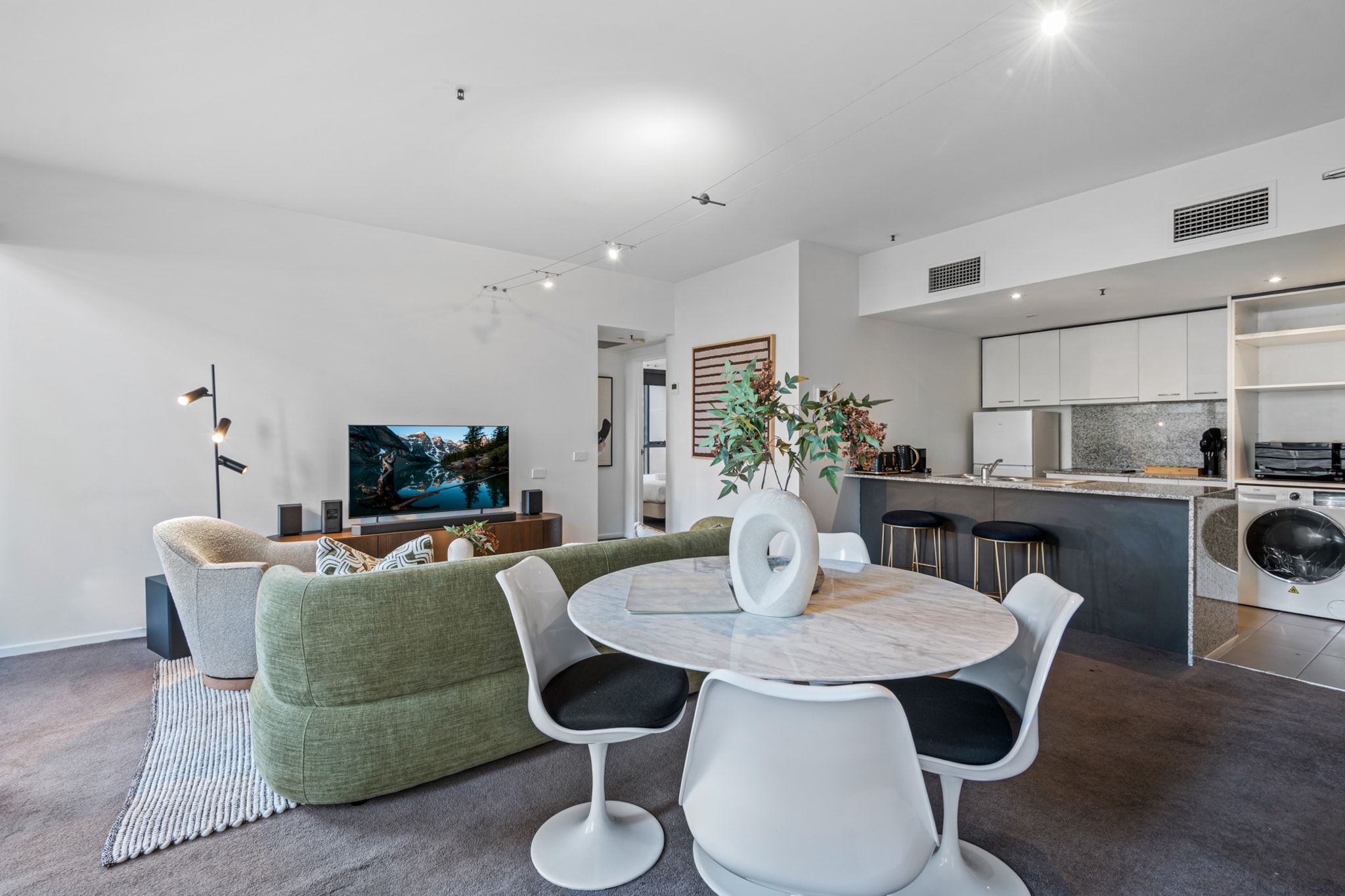 Located in the vibrant heart of Melbourne, this bright and modern 3-bedroom apartment offers a comfortable and stylish base for city explorers. With full kitchen and laundry facilities, chic furnishings, and a private balcony, it’s perfect for longer stays or quick getaways. Enjoy easy self check-in and all the essentials for a relaxing urban retreat.
The space
Step into a light-filled apartment combining urban charm with thoughtful comforts. This seventh-floor residence features three serene bedrooms with a king, queen and single bed, each fitted with blackout blinds and soft linens. The master includes a sleek en-suite, while the second bathroom caters to the remaining rooms. The open-plan living space invites relaxation with a plush 4-seater couch, coffee table, and stylish accents. A full kitchen with electric oven and stovetop makes cooking a breeze, while the dining area comfortably seats five. Step out onto the private balcony to enjoy fresh air above Melbourne’s buzzing laneways. A separate laundry with washer and dryer completes this welcoming home.
Living Room
- Couch seats 3 people + armchair
- TV with Free-to-Air (guests to use their own credentials)
Kitchen & Dining Area
- Fully equipped with cutlery and utensils
- Electric oven and electric stovetop
- Dining area seats 4, and countertop seats 2
Bathroom & Laundry
- Laundry cupboard with washer and dryer
- Travel essentials, towels and hairdryer provided
Amenity Notes
- No on-site or off-site parking available
- Ducted A/C (heating + cooling) throughout
- Wi-Fi is available
- Private balcony with outdoor furniture for 2
Local area description
Located in Melbourne’s iconic Flinders Lane precinct, this apartment is surrounded by award-winning restaurants, boutique shops, and cultural attractions. Walk to Federation Square, the NGV, or take a stroll along the Yarra River. Perfect for guests wanting to immerse themselves in Melbourne’s vibrant city lifestyle.
House rules
You are staying in a friendly and peaceful neighbourhood and we kindly ask you to respect the community and your surrounding neighbours. The following strict House Rules apply:
- No loud noise between 10 pm and 8 am
- No parties or antisocial behaviour
- No additional people are to access the property without our prior approval
- No pets are allowed in the property without approval
- No smoking is allowed at any times
- If you break something, please let us know
- To help protect all floor coverings, do not wear any shoes inside the property
Please be aware that excessive noise such as amplified music, vocals or screaming or anti-social behaviour in the property or common areas can cause neighbours to complain to us, the Building Manager, Council Rangers or Police.
IMPORTANT:
- Any breach of the House Rules may lead to a $500 fine plus compensation for any cost/damage created and immediate eviction of the property without refund.
- Pets are available on request unless the property states it is pet friendly. Any stays with pets will incur an additional cleaning fee of $200.
Finally, when checking out, we kindly ask you for the following:
- Please leave all beds unmade
- Please clean up your dishes and put them away
- In case you have rearranged furniture, please put it back to the original location
- Please take out the rubbish and remember to use the right bins
- Please ensure all appliances, A/C and lights are off and doors and windows are closed.
- Please check your accommodation thoroughly before departing to avoid any unintentional items left behind.
We are not liable for any items left behind after your stay. In the rare event that a guest reports a missing item, we will make every effort to locate it for you, but we cannot guarantee its retrieval. If the item is found, we will gladly assist in arranging its return to an address within Australia, subject to postage and service fees.
Interaction with guests
Welcome to MadeComfy! Our local team curates stays in exceptional Australian & New Zealand properties, ensuring style, comfort, and prime locations for discerning guests. We prioritise your needs to provide a memorable home-away-from-home experience. Explore our digital guidebooks for local recommendations, and don't hesitate to contact us throughout your stay. We're here to ensure your comfort - enjoy your stay with MadeComfy.
Notes
- Stairs at building entrance
For your comfort, this property is prepared with professional-grade hotel-style linen, including a three-sheet setup, ensuring a fresh and hygienic sleep experience.
Extra Services:
- Early Check-in: Our standard check-in is at 3 pm. To guarantee early access to the property we suggest booking the night before if available. Otherwise, early check-in is subject to availability from the night before at an additional cost.
- Late check-out: Our standard check-out is at 10 am. To guarantee a later check-out of the property we suggest booking an additional night if available. Otherwise, a late check-out is subject to availability from the night before to an additional cost.
- Baggage: For security reasons, we are unable to receive or to keep unattended baggage before check-in or after check-out
- We provide a small welcome amenity pack to get your stay started.
- This booking is protected with coverage for lost baggage and emergency medical expenses, provided by Travel Support with claim upto 500 AUD (T&C Applies). For more details reach out to Guest Support team post booking.
Access description
Key collection is onsite. Further details will be provided 3 days before check-in if your booking is successfully reserved.
Getting around
Public Transport
Multiple tram and bus stops within 2-min walk. Flinders Street Station is approx. 4 min walk.
Getting There
30-min drive from Melbourne Airport. Just 5 min from Melbourne CBD by car or public transport.