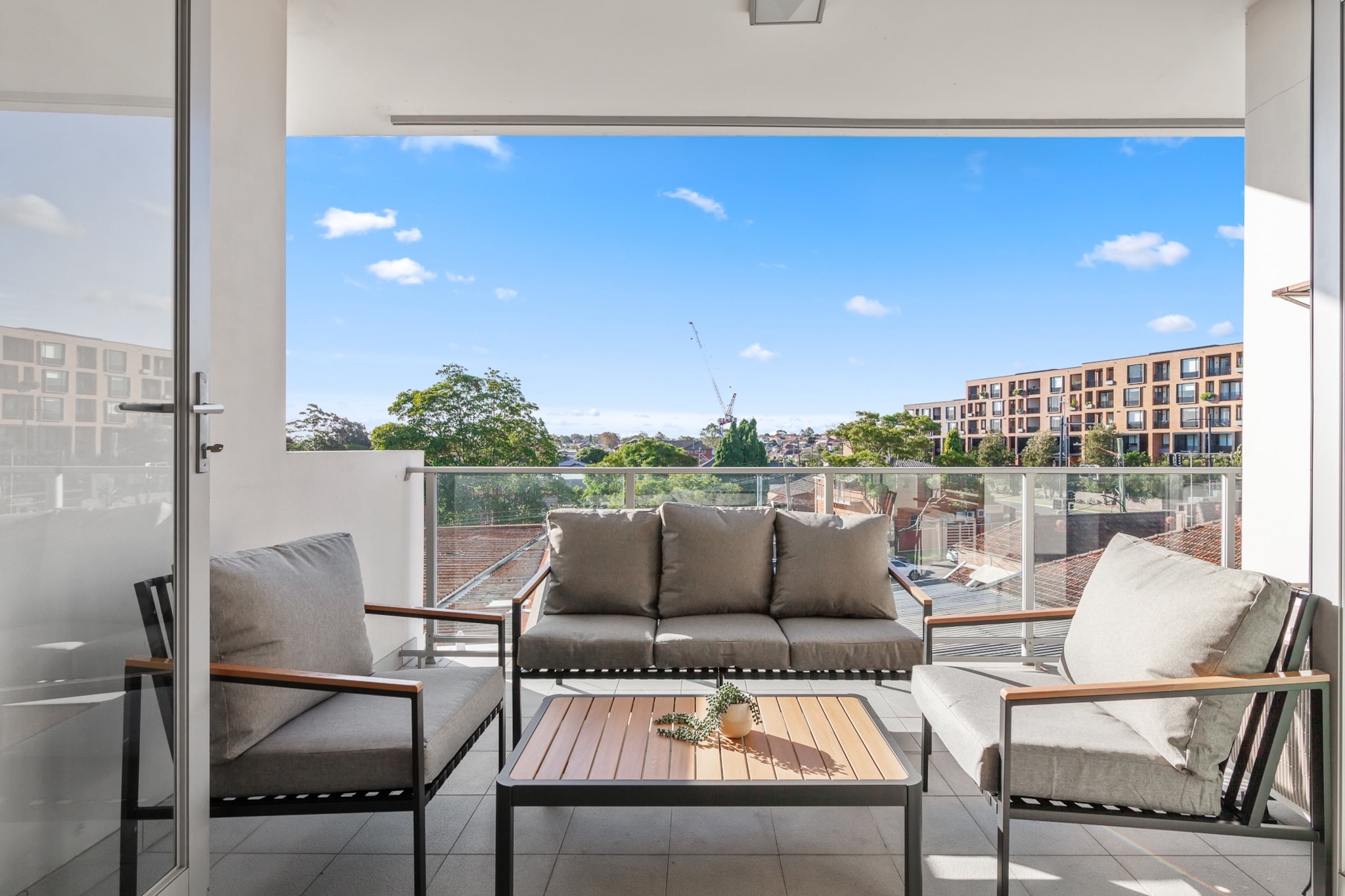 Discover this stylish 2-bedroom apartment in the heart of Five Dock. With a private balcony, onsite garage parking, and full kitchen amenities, itâ€™s ideal for business travellers or holidaymakers. Enjoy a bright living space, in-unit laundry, and seamless self check-in. Perfectly positioned near cafÃ©s, parks, and transport options.
The space
Step into this elegant and spacious apartment, where comfort meets contemporary style. The open-plan living and dining area features wooden floors, ample seating, and natural light, flowing out to a private balcony complete with a full set of outdoor furniture- perfect for morning coffees or evening unwinds. Both bedrooms are thoughtfully designed with a king & double bed, blackout blinds, bedside tables and lamps, ensuring a peaceful rest. One bedroom offers direct access to an ensuite bathroom for added privacy. The modern kitchen is fully equipped with a gas stove, oven, dishwasher, and Smeg appliances, making meal prep a breeze. The private laundry room is fitted with a washer, dryer, ironing board, and cleaning tools for your convenience. In the living area, a three-seater couch invites you to relax while enjoying the smart TV.. With thoughtful touches and all essentials provided, this retreat in the heart of Five Dock is ready to host your next Sydney stay.
 
Living Room
- Couch seats 3 people + armchair
- TV with Free-to-Air and streaming access (guests to use their own credentials)
 
Kitchen & Dining Area
- Fully equipped with cutlery and utensils
- Oven and gas stovetop
- Nespresso compatible coffee machine
- Dining area seats 4
 
Bathroom & Laundry
- Laundry room available with washer and dryer
- Travel essentials, towels and hairdryer provided
 
Amenity Notes
- Parking: Onsite garage with 2 spaces
- A/C: Air conditioning (heating + cooling) in living area only
- Ceiling fans in both bedrooms
- Study nooks in both bedrooms
- Wi-Fi is provided
- Balcony with full outdoor furniture
- Lift access is shared with minimal other residents in the building (making it quick and easy to use the lift)
Local area description
Located in vibrant Five Dock, this apartment offers easy access to local cafÃ©s, shops, and waterfront parks. Enjoy the relaxed suburban lifestyle just 10km from Sydney CBD. Visit the popular Bay Run, explore Barnwell Park Golf Course, or sample delicacies at the Italian delis nearby.