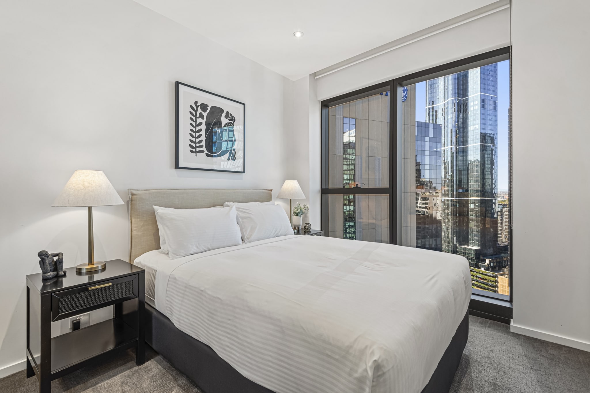 Property description
Relax in this stylish Southbank apartment featuring two comfortable bedrooms, a sunlit living area, and a private balcony. Ideal for professionals or families, it includes a full kitchen, laundry, and ducted A/C. Enjoy entertainment with a streaming-ready TV and easy self-check-in via Keynest. Located near the Crown Complex and Yarra River, it offers a perfect base for exploring Melbourneâ€™s cultural heart.

The space
Step into a sleek Southbank retreat where comfort meets convenience. This two-bedroom apartment features queen beds dressed in soft linens, blackout blinds, and ample storage. The open-plan living area includes a cozy 3-seater couch, coffee table, and rug, offering a relaxing space to unwind with your favorite streaming shows. A stylish dining space for four adjoins the kitchen, fully equipped with modern appliances, including a gas stovetop, electric oven, and a coffee machine. The private balcony, accessed via the lounge, invites you to take in urban views. The home includes a bathroom with essential amenities and a private laundry with washer, dryer, ironing gear, and clothes drying rack. Thoughtful touches like decorative styling and artificial plants enhance the ambience.