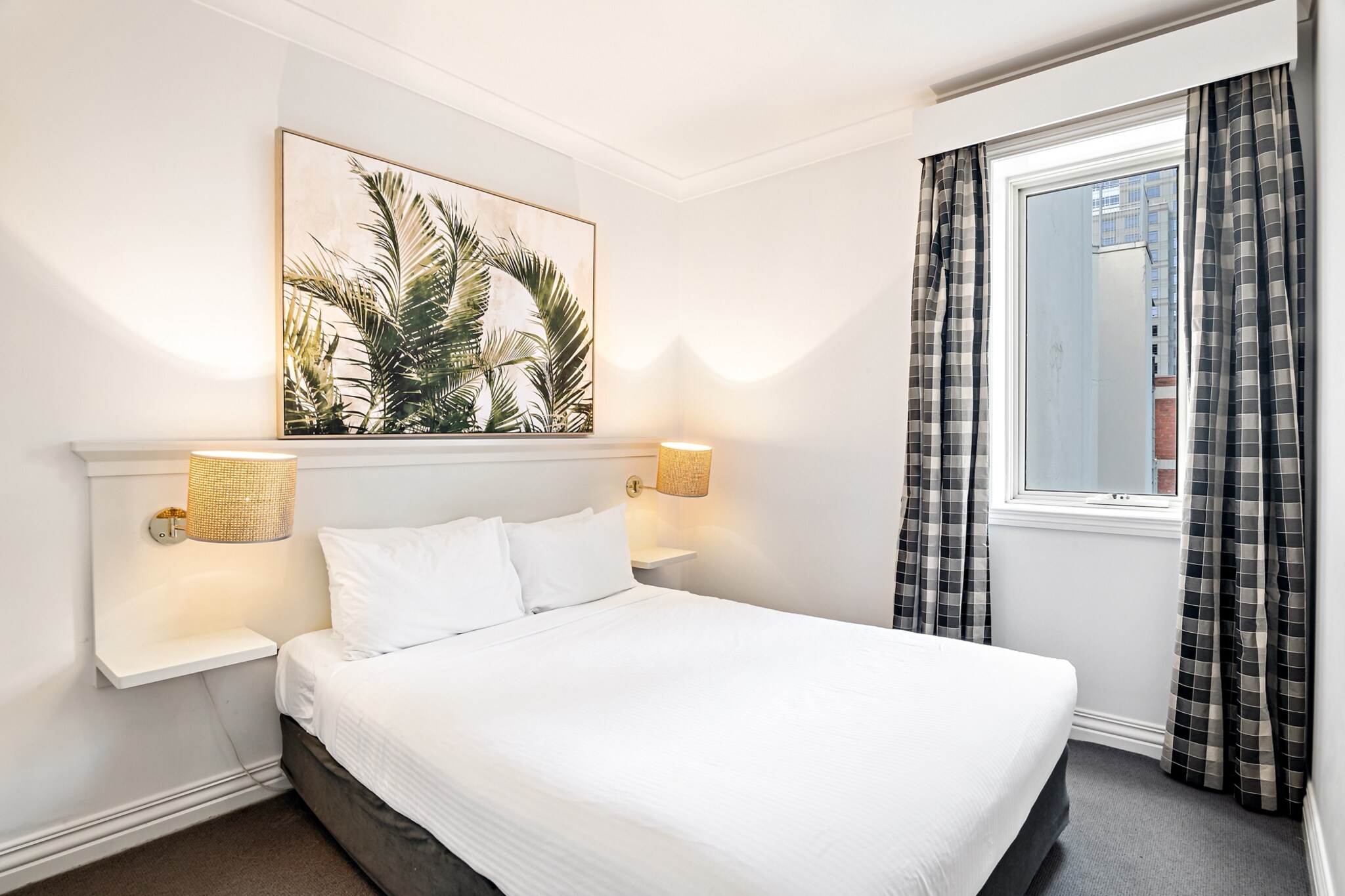 Experience Melbourne from a well-located apartment on Collins Street, steps from theatres, shopping, and laneway cafÃ©s. This one-bedroom space offers a double bed, a dedicated working desk, and a fully equipped kitchen. Perfect for solo travellers or couples. Enjoy self-check-in and easy access to city attractions.
The space
Located on the seventh floor, this inner-city apartment combines city convenience with comfort. The living space features a couch/sofa bed, a coffee table, carpeted floors, and a TV. The kitchen is equipped with essentials, featuring an electric stovetop, microwave, dishwasher, coffee machine, and kitchenware. The bedroom includes a double bed, bedside tables, lamps, and storage. The bathroom is fitted with a shower, toilet, hairdryer, and fresh towels. There's also a work desk in the living area, perfect for planning your Melbourne itinerary. With its unbeatable location in Melbourneâ€™s cultural core, this apartment makes a smart and suitable base.
 
Living Room
- Couch seats 2 people + armchair
- TV with Free-to-Air access
- Sofa bed for 1 additional guest
 
Kitchen & Dining Area
- Fully equipped with cutlery and utensils
- Electric stovetop and microwave
- Dining area seats 2
- Fridge
 
Bathroom
- Travel essentials, towels and hairdryer provided
- Iron and ironing board
- Communal tap-and-go laundry room available (additional charges apply)
 
Amenity Notes
- There is no parking available, and the area can be difficult to park in. We recommend using the free tram loop, which stops directly on Collins Street
- A/C (heating + cooling) in the living area only
- Work desk located in the living area
- WiFi available via QR code