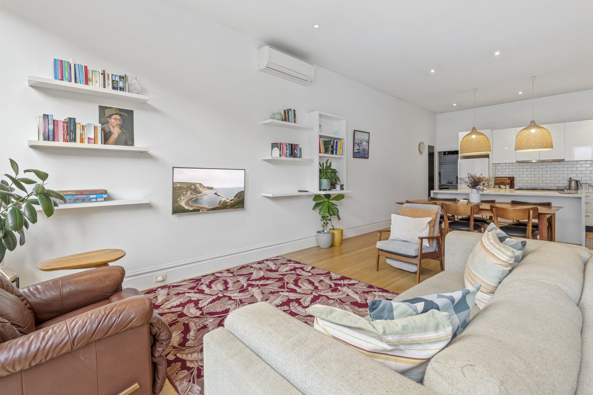 Unwind in this light-filled 2-bed Kensington home featuring a private courtyard, chic furnishings, and a fully equipped kitchen. Ideal for families or friends, enjoy stylish interiors, modern appliances, and a vibrant neighbourhood close to cafes, parks, and public transport. Just a 5-minute walk to Macaulay Station and within close proximity to the Melbourne Zoo.
The space
This charming two-bedroom home offers a harmonious blend of comfort and style. The spacious living room, with a 5-seater couch, opens to an inviting courtyard perfect for alfresco moments. Bedrooms are fitted with queen beds, blackout blinds, and ambient lighting for restful nights. The kitchen features gas cooking and an electric oven, flowing into a 6-seat dining space and a breakfast bar. Hardwood floors, decorative touches, and a serene palette elevate the homeâ€™s aesthetic. A single bathroom supports your stay, while a private laundry with washer and dryer adds convenience. A peaceful retreat, yet close to the bustle of Kensingtonâ€™s popular spots.
 
Living Room
-Couch seats 5 people
-TV with Free-to-Air and streaming access (guests to use their own credentials)
 
Kitchen & Dining Area
-Fully equipped with cutlery and utensils
-Oven and gas stovetop and electric oven
-Dining area seats 6 and countertop seats 3
 
Bathroom & Laundry
-Laundry room available with washer and dryer
-Travel essentials, towels and hairdryer provided
 
Amenity Notes
-Parking: Free street parking only
-A/C in living and kitchen areas
-Wi-Fi is available
-Private outdoor courtyard with full outdoor furniture
-The fireplace is for decoration purposes only
Local area description
Located in Kensington, a leafy suburb just 4km from Melbourne CBD, this home offers a village vibe with city convenience. Stroll to local cafÃ©s, explore nearby JJ Holland Park, or catch events at Flemington Racecourse. Enjoy a balance of quiet streets and vibrant culture.
House rules
You are staying in a friendly and peaceful neighbourhood and we kindly ask you to respect the community and your surrounding neighbours. The following strict House Rules apply:
 
- No loud noise between 10 pm and 8 am
- No parties or antisocial behaviour
- No additional people are to access the property without our prior approval
- No pets are allowed in the property without approval
- No smoking is allowed at any times
- If you break something, please let us know
- To help protect all floor coverings, do not wear any shoes inside the property
 
Please be aware that excessive noise such as amplified music, vocals or screaming or anti-social behaviour in the property or common areas can cause neighbours to complain to us, the Building Manager, Council Rangers or Police.
 
IMPORTANT:
- Any breach of the House Rules may lead to a $500 fine plus compensation for any cost/damage created and immediate eviction of the property without refund.
- Pets are available on request unless the property states it is pet friendly. Any stays with pets will incur an additional cleaning fee of $200.
 
Finally, when checking out, we kindly ask you for the following:
 
- Please leave all beds unmade
- Please clean up your dishes and put them away
- In case you have rearranged furniture, please put it back to the original location
- Please take out the rubbish and remember to use the right bins
- Please ensure all appliances, A/C and lights are off and doors and windows are closed.
- Please check your accommodation thoroughly before departing to avoid any unintentional items left behind.
 
We are not liable for any items left behind after your stay. In the rare event that a guest reports a missing item, we will make every effort to locate it for you, but we cannot guarantee its retrieval. If the item is found, we will gladly assist in arranging its return to an address within Australia, subject to postage and service fees.
Interaction with guests
Welcome to MadeComfy! Our local team curates stays in exceptional Australian & New Zealand properties, ensuring style, comfort, and prime locations for discerning guests. We prioritise your needs to provide a memorable home-away-from-home experience. Explore our digital guidebooks for local recommendations, and don't hesitate to contact us throughout your stay. We're here to ensure your comfort - enjoy your stay with MadeComfy.
Notes
For your comfort, this property is prepared with professional-grade hotel-style linen, including a three-sheet setup, ensuring a fresh and hygienic sleep experience.
 
Extra Services:
- Early Check-in: Our standard check-in is at 3 pm. To guarantee early access to the property we suggest booking the night before if available. Otherwise, early check-in is subject to availability from the night before at an additional cost.
- Late check-out: Our standard check-out is at 10 am. To guarantee a later check-out of the property we suggest booking an additional night if available. Otherwise, a late check-out is subject to availability from the night before to an additional cost.
- Baggage: For security reasons, we are unable to receive or to keep unattended baggage before check-in or after check-out
- We provide a small welcome amenity pack to get your stay started.
- This booking is protected with coverage for lost baggage and emergency medical expenses, provided by Travel Support with claim upto 500 AUD (T&C Applies). For more details reach out to Guest Support team post booking.
Access description
Key collection is onsite. Further details will be provided 3 days before check-in if your booking is successfully reserved.
Getting around
Public Transport
Kensington Station is a 5-min walk and connects via Craigieburn line. Multiple bus stops within 3â€“5 min walk.
 
Getting There
Approx. 20 mins (25 km) from Melbourne Airport by car. Just 15 mins (4 km) drive or train from Melbourne CBD.