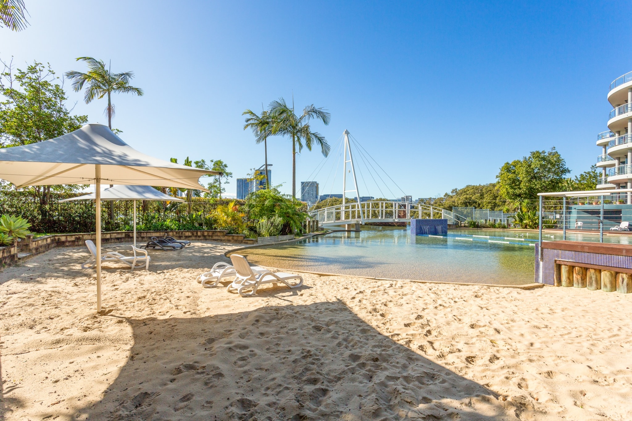 Enjoy a relaxing stay in this spacious 2-bedroom apartment in Wentworth Point, featuring a private balcony, access to a outdoor pool, gym and sauna, and a full kitchen. Perfect for couples, small families, or business travelers, it also features a full kitchen, one bathroom, and onsite parking. Self-check-in is available.

The space
Located along the banks of Homebush Bay, this stylish apartment offers a perfect base just minutes from Sydney Olympic Park, Qudos Bank Arena, URBNSURF, and Sydney Showground. Set in a vibrant neighbourhood with cafÃ©s, restaurants, and shops, itâ€™s ideal for event stays, weekend getaways, or longer visits. The apartment features a bright open-plan living and dining area, a private balcony with outdoor seating, and two well-appointed bedrooms (king and double). Guests can enjoy a fully equipped kitchen, spacious bathroom, and a separate laundry with washer and dryer. With natural light throughout and self-check-in for added convenience, the space is designed for comfort, ease, and a great location experience.
 
Living Room
- L-Shaped couch seats 4 people + armchair
- TV with Free-to-Air and streaming access (guests to use their own credentials)
 
Kitchen & Dining Area
- Fully equipped with cutlery and utensils
- Gas stovetop, oven and coffee machine
- Dining area seats 4
 
Bathroom & Laundry
- Laundry room available with washer and dryer
- Travel essentials, towels and hairdryer provided
 
Amenity Notes
- Onsite parking in garage (1 space)
- Split A/C (heating + cooling) in the living room
- 2 portable fans available
- Wi-Fi is available
- Balcony with outdoor furniture and views over Olympic Archery
- Communal outdoor pool/sand beach pool, gym and sauna in the building
Local area description
Wentworth Point offers a relaxed riverside lifestyle with parks, cafÃ©s, and walking trails at your doorstep. Explore nearby Sydney Olympic Park, stroll along the foreshore, or shop and dine at Marina Square. Enjoy waterfront tranquillity while being just minutes from vibrant local attractions.
ocal area description
Wentworth Point offers a relaxed riverside lifestyle with parks, cafÃ©s, and walking trails at your doorstep. Explore nearby Sydney Olympic Park, stroll along the foreshore, or shop and dine at Marina Square. Enjoy waterfront tranquillity while being just minutes from vibrant local attractions.
 
Key Nearby Attractions:
Qudos Bank Arena â€“ 2 km
Sydney Showground & Easter Show â€“ 1.8 km
URBNSURF Sydney â€“ 2 km
Olympic Park Ferry Wharf â€“ 4 km
Marina Square Shopping Centre â€“ 4 km
Newington Armory & Blaxland Riverside Park â€“ 5.5 km
House rules
You are staying in a friendly and peaceful neighbourhood and we kindly ask you to respect the community and your surrounding neighbours. The following strict House Rules apply:
 
- No loud noise between 10 pm and 8 am
- No parties or antisocial behaviour
- No additional people are to access the property without our prior approval
- No pets are allowed in the property without approval
- No smoking is allowed at any times
- If you break something, please let us know
- To help protect all floor coverings, do not wear any shoes inside the property
 
Please be aware that excessive noise such as amplified music, vocals or screaming or anti-social behaviour in the property or common areas can cause neighbours to complain to us, the Building Manager, Council Rangers or Police.
 
IMPORTANT:
- Any breach of the House Rules may lead to a $500 fine plus compensation for any cost/damage created and immediate eviction of the property without refund.
- Pets are available on request unless the property states it is pet friendly. Any stays with pets will incur an additional cleaning fee of $200.
 
Finally, when checking out, we kindly ask you for the following:
 
- Please leave all beds unmade
- Please clean up your dishes and put them away
- In case you have rearranged furniture, please put it back to the original location
- Please take out the rubbish and remember to use the right bins
- Please ensure all appliances, A/C and lights are off and doors and windows are closed.
- Please check your accommodation thoroughly before departing to avoid any unintentional items left behind.
 
We are not liable for any items left behind after your stay. In the rare event that a guest reports a missing item, we will make every effort to locate it for you, but we cannot guarantee its retrieval. If the item is found, we will gladly assist in arranging its return to an address within Australia, subject to postage and service fees.
Interaction with guests
Welcome to MadeComfy! Our local team curates stays in exceptional Australian & New Zealand properties, ensuring style, comfort, and prime locations for discerning guests. We prioritise your needs to provide a memorable home-away-from-home experience. Explore our digital guidebooks for local recommendations, and don't hesitate to contact us throughout your stay. We're here to ensure your comfort - enjoy your stay with MadeComfy.
Notes
For your comfort, this property is prepared with professional-grade hotel-style linen, including a three-sheet setup, ensuring a fresh and hygienic sleep experience.
 
Property has long-term stay discounts available for stays over 21 days (please enquire for further details)
 
Extra Services:
- Early Check-in: Our standard check-in is at 3 pm. To guarantee early access to the property we suggest booking the night before if available. Otherwise, early check-in is subject to availability from the night before at an additional cost.
- Late check-out: Our standard check-out is at 10 am. To guarantee a later check-out of the property we suggest booking an additional night if available. Otherwise, a late check-out is subject to availability from the night before to an additional cost.
- Baggage: For security reasons, we are unable to receive or to keep unattended baggage before check-in or after check-out
- We provide a small welcome amenity pack to get your stay started.
- This booking is protected with coverage for lost baggage and emergency medical expenses, provided by Travel Support with claim upto 500 AUD (T&C Applies). For more details reach out to Guest Support team post booking.
Access description
Key collection is onsite. Further details will be provided 3 days before check-in if your booking is successfully reserved.
Getting around
Public Transport
Bus routes operate frequently through Wentworth Point. Nearby Olympic Park station connects to train lines across Sydney.
 
Getting There
Sydney CBD is approx. 35 mins by car. From Sydney Airport, expect around 40â€“45 mins by car or taxi.
