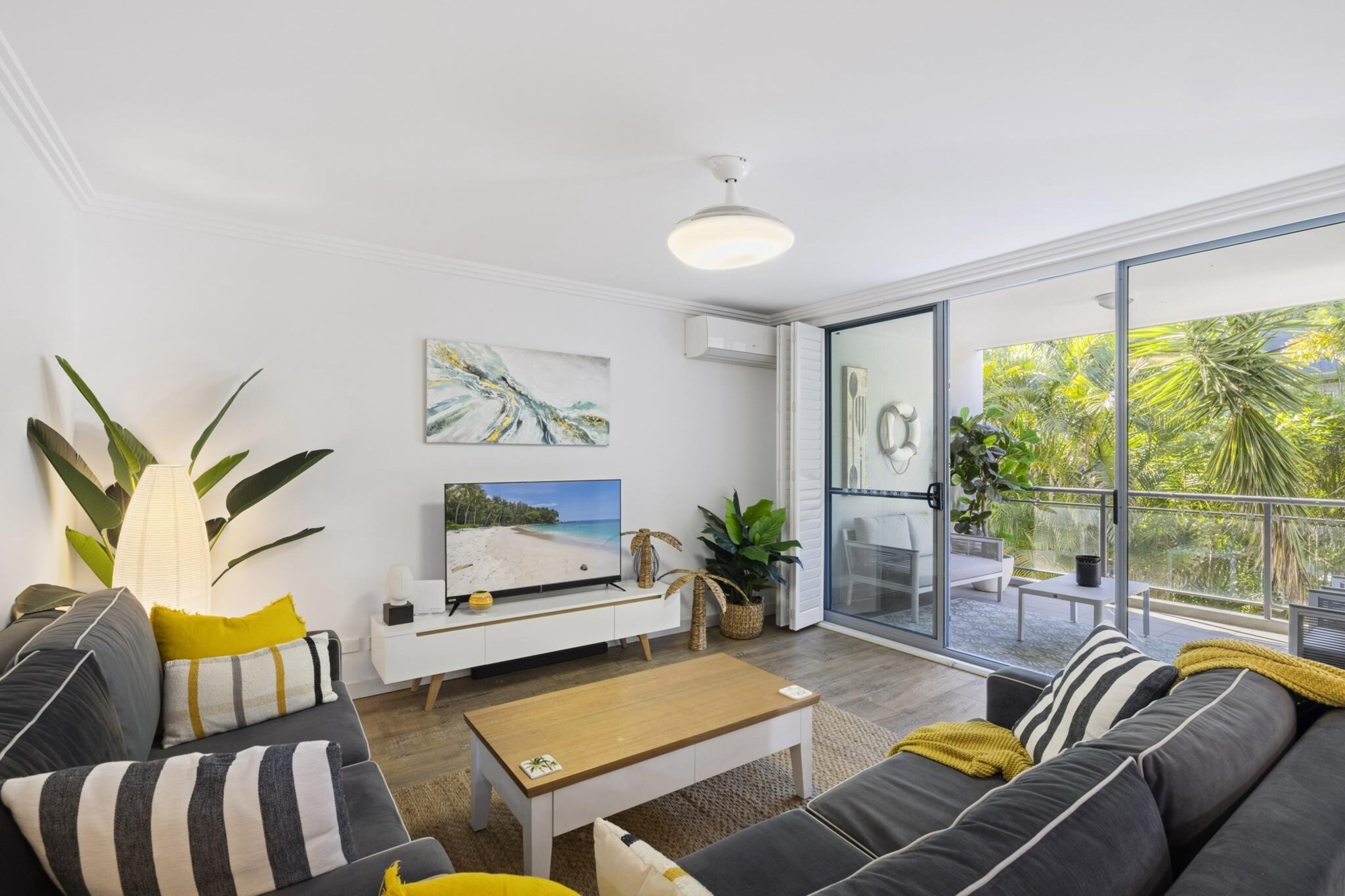Enjoy this bright and stylish 2-bedroom apartment in scenic Narrabeen. Just minutes from the beach, it features a fully equipped kitchen, private balcony with BBQ, comfortable lounge, and self-check-in. Ideal for families or couples, with garage parking and all essentials provided for a relaxed stay.
The space
Step into a thoughtfully styled coastal apartment designed for comfort and ease. The interiors blend warmth and simplicity with natural wooden floors, soft lighting, and inviting furnishings throughout. The spacious living area offers a 5-seater couch, Smart TV, and access to a breezy balcony with outdoor seating and a gas BBQ — perfect for slow evenings by the sea breeze.
Both bedrooms feature queen beds with plantation shutters, bedside tables, and ample storage, with the master enjoying a private en-suite. A second modern bathroom adds extra convenience for families or groups. The kitchen is sleek and fully equipped with a gas stovetop, electric oven, dishwasher, and generous dining space for up to 8.
A separate laundry with washer and dryer is discreetly tucked away, while Wi-Fi and garage parking add to the practical perks. Ceiling fans, a gas heater, and A/C in the living room ensure comfort year-round. This relaxed beachside retreat is a seamless blend of laid-back coastal charm and everyday functionality.
Living Room
-Couch seats 5 people
-TV with streaming apps (guests to use their own credentials)
Kitchen & Dining Area
-Fully equipped with cutlery, and utensils
-Electric oven and gas stovetop
-Dining area seats 8 and countertop seats 2
Bathroom & Laundry
-Laundry room available with washer and dryer
-Travel essentials, towels and hairdryer provided
Amenity Notes
-Onsite parking in secure garage for 1 normal-sized car
-A/C (cooling) in living room, fans in bedrooms and lounge
-Gas heater in living room
-Wi-Fi is available
-Private BBQ and outdoor seating on balcony
-Travel Cot
Local area description
Located in beautiful Narrabeen, this apartment is just a short stroll from golden beaches, cafés, and scenic lakeside walks. Enjoy the relaxed Northern Beaches lifestyle with nearby Narrabeen Lagoon, Warriewood Square for shopping, and popular surf spots along the coast. Perfect for families or couples seeking sun, surf, and serenity.
House rules
You are staying in a friendly and peaceful neighbourhood and we kindly ask you to respect the community and your surrounding neighbours. The following strict House Rules apply:
- No loud noise between 10 pm and 8 am
- No parties or antisocial behaviour
- No additional people are to access the property without our prior approval
- No pets are allowed in the property without approval
- No smoking is allowed at any times
- If you break something, please let us know
- To help protect all floor coverings, do not wear any shoes inside the property
Please be aware that excessive noise such as amplified music, vocals or screaming or anti-social behaviour in the property or common areas can cause neighbours to complain to us, the Building Manager, Council Rangers or Police.
IMPORTANT:
- Any breach of the House Rules may lead to a $500 fine plus compensation for any cost/damage created and immediate eviction of the property without refund.
- Pets are available on request unless the property states it is pet friendly. Any stays with pets will incur an additional cleaning fee of $200.
Finally, when checking out, we kindly ask you for the following:
- Please leave all beds unmade
- Please clean up your dishes and put them away
- In case you have rearranged furniture, please put it back to the original location
- Please take out the rubbish and remember to use the right bins
- Please ensure all appliances, A/C and lights are off and doors and windows are closed.
- Please check your accommodation thoroughly before departing to avoid any unintentional items left behind.
We are not liable for any items left behind after your stay. In the rare event that a guest reports a missing item, we will make every effort to locate it for you, but we cannot guarantee its retrieval. If the item is found, we will gladly assist in arranging its return to an address within Australia, subject to postage and service fees.
Interaction with guests
Welcome to MadeComfy! Our local team curates stays in exceptional Australian & New Zealand properties, ensuring style, comfort, and prime locations for discerning guests. We prioritise your needs to provide a memorable home-away-from-home experience. Explore our digital guidebooks for local recommendations, and don't hesitate to contact us throughout your stay. We're here to ensure your comfort - enjoy your stay with MadeComfy.
Notes
- Stairs are required to reach the unit
- Please note that on Monday 29th September Canopy Constructions will be onsite installing scaffolding and will need to partially block part of the drive way from 7am on Monday 29/09/26.