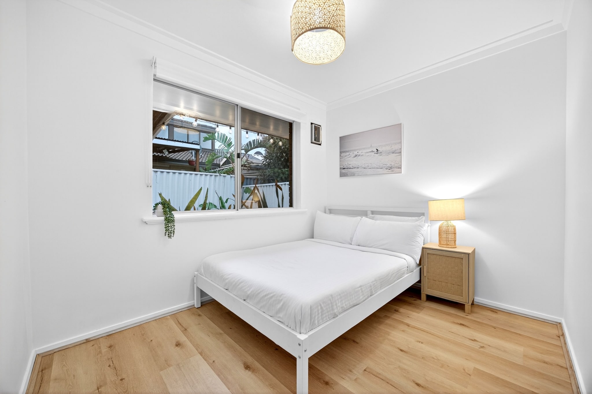 Property description
Enjoy a coastal escape in this bright 2-bed unit in Scarborough. Perfect for families or small groups, it features stylish interiors, a well-equipped kitchen, outdoor seating, and onsite parking. Stay comfortable with reverse cycle air conditioning, unwind with Free-to-Air and streaming apps on the TV, and enjoy the convenience of easy self-check-in.
The space
Step into this inviting Scarborough retreat, where sunlight fills the thoughtfully styled interior. The unit offers two comfortable bedrooms—one with a double bed and the other with two single beds—each fitted with blackout blinds for restful sleep. The shared bathroom also serves as a private laundry area, opening to an outdoor space complete with a full outdoor furniture set for breezy relaxation. In the living area, a cozy two-seater lounge and soft rug sit atop vinyl flooring, complemented by a TV, along with stylish decorative accents. The kitchen and dining area are well-appointed with modern appliances, plus a coffee machine and microwave. A reverse cycle A/C in the living room provides both heating and cooling for year-round comfort. With onsite parking, this unit offers everything needed for a fuss-free beachside getaway.