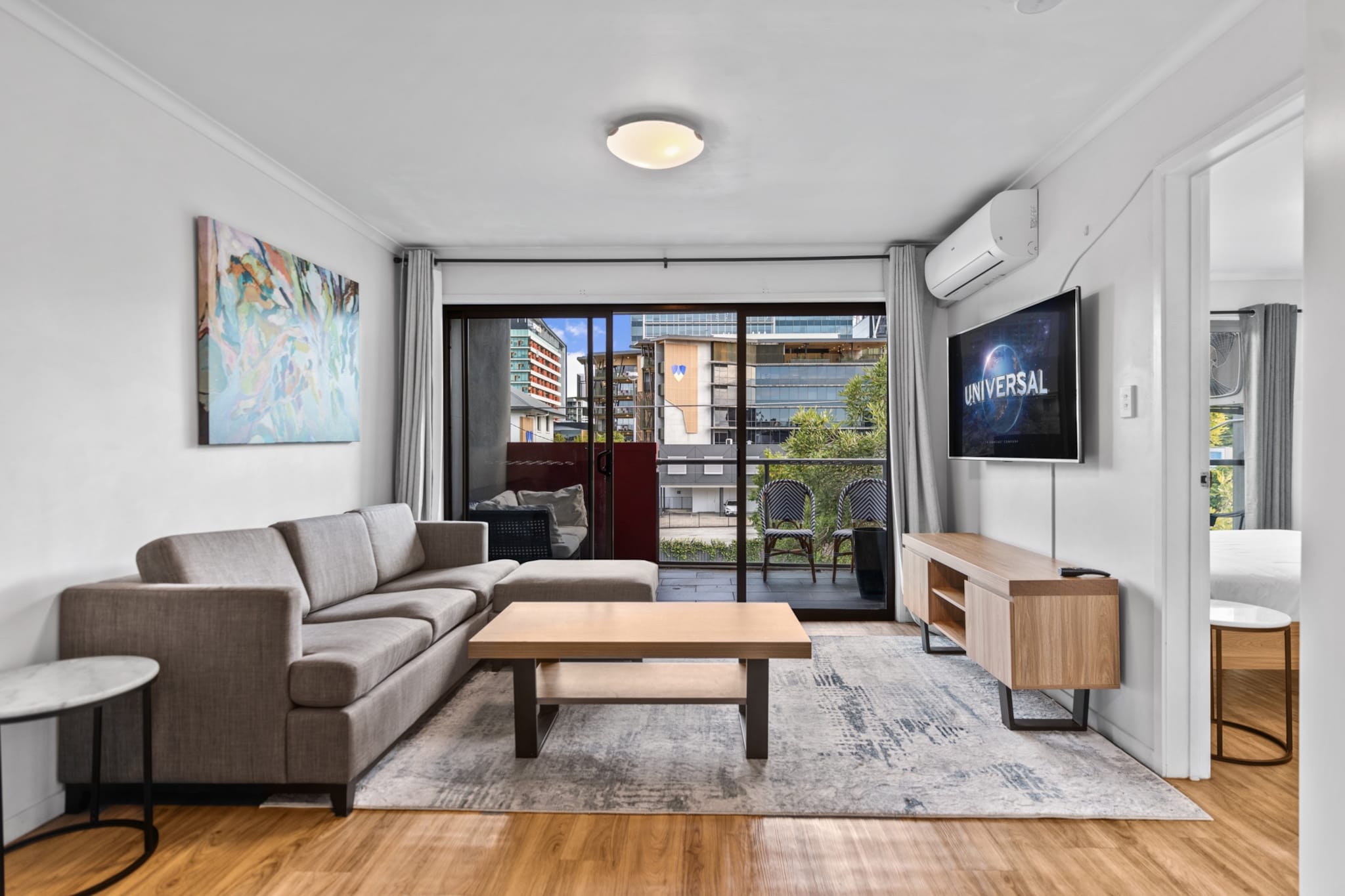 Enjoy a vibrant Bowen Hills stay in this stylish one-bedroom unit. With secure parking, a private balcony, and access to a communal pool, this apartment offers ideal comfort near Brisbaneâ€™s best attractions. Perfect for solo travellers or couples, the space is fully equipped with modern appliances and split A/C. Enjoy keyless entry and Wi-Fi for a seamless stay.
The space
Step into a bright, centrally located apartment designed for comfort and convenience. The unit features a queen-size bed with soft linens and blackout blinds in the bedroom, providing a comfortable and restful sleep environment. A modern en-suite bathroom adds convenience and style to the space. The open-plan living and dining area is furnished with a three-seater couch, smart TV with streaming options, and a timber-look floor, enhancing the inviting aesthetic. A dining table with four seats and a breakfast bar with two stools make it easy to entertain or work from home. The kitchen is fully stocked with cookware, an electric stovetop, oven, and dishwasher for effortless meal prep. Step outside to a private balcony furnished for relaxed outdoor lounging.
 
Living Room
- Couch seats 3 people
- TV with streaming apps (guests to use their own credentials)
 
Kitchen & Dining Area
- Fully equipped with cutlery and utensils
- Electric oven and electric stovetop
- Dining area seats 4 and countertop seats 2
 
Bathroom & Laundry
- Guests to use a nearby laundromat for laundry needs
- Travel essentials, towels and hairdryer provided
 
Amenity Notes
- Onsite secure parking for 1 medium car
- Split system A/C (heating + cooling) in living and bedroom
- Wi-Fi is available
- Private Amenities: Furnished balcony
- Building Amenities: Communal pool on LG floor, BBQ and gym
- No laundry facilities available
Local area description
Located in vibrant Bowen Hills, this apartment offers easy access to Brisbaneâ€™s entertainment precincts and dining hubs. Enjoy a short walk to King Streetâ€™s trendy cafÃ©s, explore RNA Showgrounds, or catch a show at Brisbane Showgrounds. Ideal for city exploration with a relaxed suburban vibe.
House rules
You are staying in a friendly and peaceful neighbourhood and we kindly ask you to respect the community and your surrounding neighbours. The following strict House Rules apply:
 
- No loud noise between 10 pm and 8 am
- No parties or antisocial behaviour
- No additional people are to access the property without our prior approval
- No pets are allowed in the property without approval
- No smoking is allowed at any times
- If you break something, please let us know
- To help protect all floor coverings, do not wear any shoes inside the property
 
Please be aware that excessive noise such as amplified music, vocals or screaming or anti-social behaviour in the property or common areas can cause neighbours to complain to us, the Building Manager, Council Rangers or Police.
 
IMPORTANT:
- Any breach of the House Rules may lead to a $500 fine plus compensation for any cost/damage created and immediate eviction of the property without refund.
- Pets are available on request unless the property states it is pet friendly. Any stays with pets will incur an additional cleaning fee of $200.
 
Finally, when checking out, we kindly ask you for the following:
 
- Please leave all beds unmade
- Please clean up your dishes and put them away
- In case you have rearranged furniture, please put it back to the original location
- Please take out the rubbish and remember to use the right bins
- Please ensure all appliances, A/C and lights are off and doors and windows are closed.
- Please check your accommodation thoroughly before departing to avoid any unintentional items left behind.
 
We are not liable for any items left behind after your stay. In the rare event that a guest reports a missing item, we will make every effort to locate it for you, but we cannot guarantee its retrieval. If the item is found, we will gladly assist in arranging its return to an address within Australia, subject to postage and service fees.
Interaction with guests
Welcome to MadeComfy! Our local team curates stays in exceptional Australian & New Zealand properties, ensuring style, comfort, and prime locations for discerning guests. We prioritise your needs to provide a memorable home-away-from-home experience. Explore our digital guidebooks for local recommendations, and don't hesitate to contact us throughout your stay. We're here to ensure your comfort - enjoy your stay with MadeComfy.
Notes
- Pets allowed upon approved requests; additional fees apply
 
For your comfort, this property is prepared with professional-grade hotel-style linen, including a three-sheet setup, ensuring a fresh and hygienic sleep experience.
 
Extra Services:
- Early Check-in: Our standard check-in is at 3 pm. To guarantee early access to the property we suggest booking the night before if available. Otherwise, early check-in is subject to availability from the night before at an additional cost.
- Late check-out: Our standard check-out is at 10 am. To guarantee a later check-out of the property we suggest booking an additional night if available. Otherwise, a late check-out is subject to availability from the night before to an additional cost.
- Baggage: For security reasons, we are unable to receive or to keep unattended baggage before check-in or after check-out
- We provide a small welcome amenity pack to get your stay started.
- This booking is protected with coverage for lost baggage and emergency medical expenses, provided by Travel Support with claim upto 500 AUD (T&C Applies). For more details reach out to Guest Support team post booking.
Access description
Key collection is onsite. Further details will be provided 3 days before check-in if your booking is successfully reserved.
Getting around
Public Transport
Bowen Hills Station is a 5-min walk, connecting to trains and buses across Brisbane. Several bus stops are within 3â€“5 min walking distance.
 
Getting There
Brisbane Airport is approx. 15 min (13 km) by car. Brisbane CBD is 10 min (4 km) away by car or train.