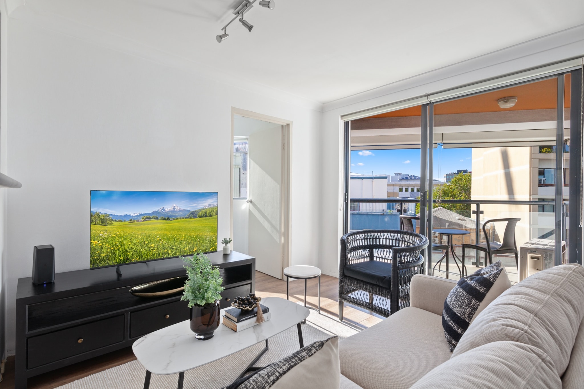 Discover comfort and convenience in this modern 2-bedroom Surry Hills apartment. Just steps from Central Station, enjoy a well-equipped kitchen, private balcony, and secure parking. Ideal for city getaways, business stays, or exploring Sydneyâ€™s lively dining scene. Self-check-in via onsite lockbox ensures a smooth arrival.

The space
Step inside this bright sixth-floor apartment where a fresh, modern design welcomes you into the heart of Surry Hills. The living area is furnished with a plush 4-seater couch, warm wood floors, and a sleek TV unit for streaming your favourite platforms. Two queen bedrooms offer soft bedding, bedside tables, and ample lighting, with blackout blinds ensuring restful sleep. The bathroom, though older in style, is clean and functional, featuring all travel essentials. The compact kitchen includes everything needed for home cooking, from a gas stovetop and electric oven to a full dining setting. A private balcony extends off the living area with stylish outdoor furniture, perfect for your morning coffee or evening wine. The private laundry, complete with washer and dryer, adds to your convenience.
 
Living Room
- Couch seats 4 people
- TV with digital platforms
 
Kitchen & Dining Area
- Fully equipped with cutlery and utensils
- Electric oven and gas stovetop
- Dining area seats 4
 
Bathroom & Laundry
- Laundry room available with washer and dryer
- Travel essentials, towels and hairdryer provided
 
Amenity Notes
- Onsite parking in common garage (spot #47, standard car size)
- Bedroom 1: A/C (heating + cooling), both rooms have portable heater/fan units
- Wi-Fi is available
- Private balcony with outdoor furniture
