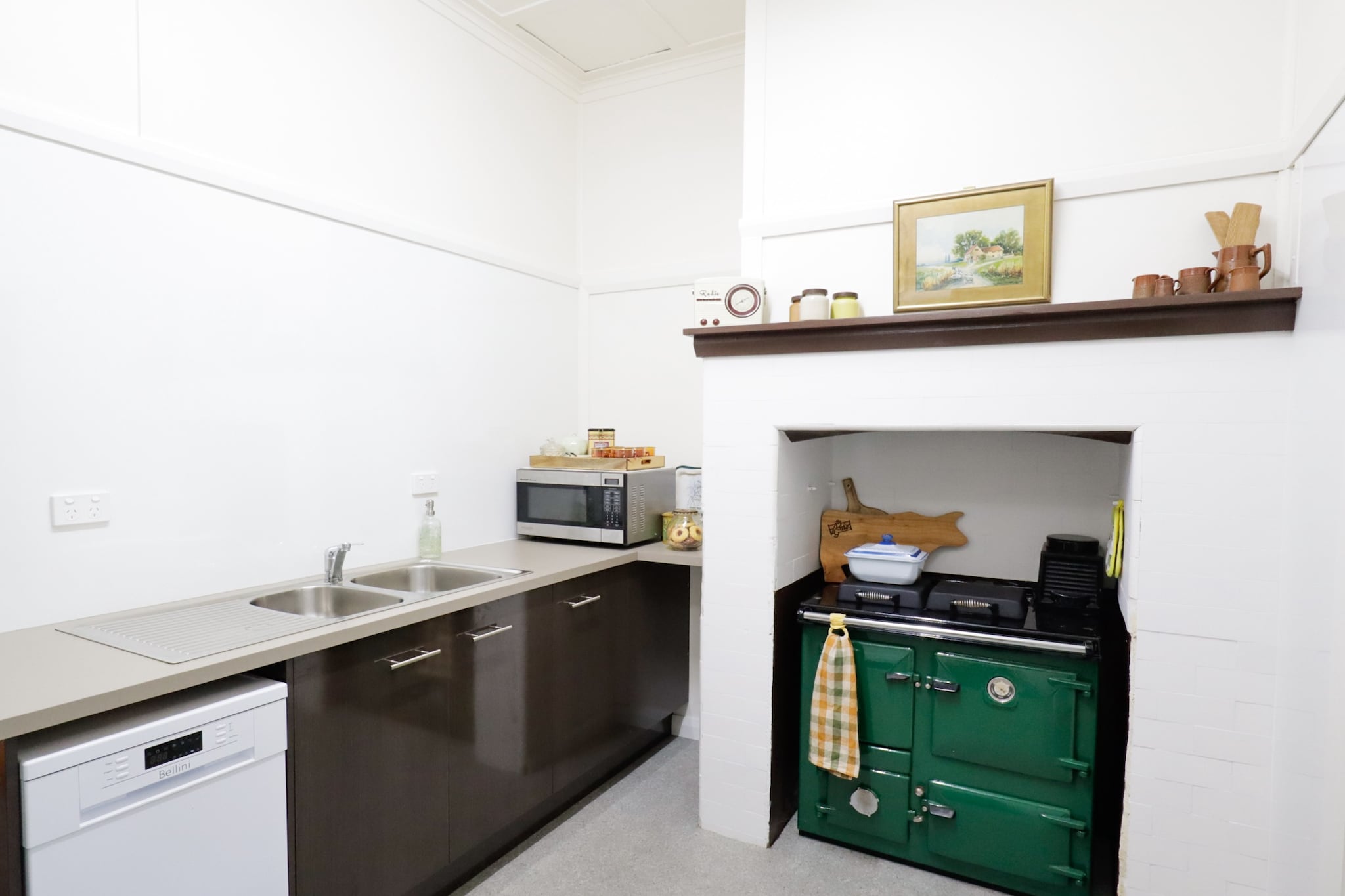 Set in the heart of Tenterfield, this 3-bedroom home is perfect for families or groups. With queen beds, two bathrooms, a full kitchen, fireplace, A/C, and Wi-Fi, itâ€™s ideal year-round. Enjoy BBQs in the fenced backyard or stroll next door to the local tavern. Whether relaxing indoors or exploring nearby landmarks, this cosy retreat offers a peaceful and convenient base for your getaway.
The space
Blending modern comfort with country charm, this 3-bedroom, 2-bath home is thoughtfully designed for a relaxed stay. Each bedroom features a plush queen bed and storage, while both bathrooms are stocked with essentials, and one includes a bathtub for a soothing soak. The kitchen is fully equipped with a dishwasher, espresso machine, and all the cookware needed for home-style meals. Gather in the inviting living room by the fireplace or relax outdoors in the sunny, fully fenced backyard, perfect for pets and families. The covered patio includes a BBQ grill, dining set, and sun loungersâ€”ideal for lazy afternoons or entertaining into the evening. A single-car garage and street parking ensure easy access, while ceiling fans, radiant heaters, and A/C keep the home comfortable in any season. Located steps from the Tenterfield Tavern and minutes from local attractions, this charming home offers a peaceful escape with all the convenience of town living.
 
Living Room
- Couch seats 6 people
- TV with streaming (guests to use their own credentials)
- Indoor fireplace
 
Bedrooms:
- Electric blankets
 
Kitchen & Dining Area
- Fully equipped with cookware, cutlery, and utensils
- Oven and electric stovetop
- Dining area seats 6
 
Bathroom & Laundry
- Laundry room available with a washer only
- Travel essentials, towels and hairdryer provided
 
Amenity Notes
- On-site parking in single-car garage
- A/C & ceiling fan in living area
- Ceiling fans and heaters in bedrooms
- Wi-Fi is available
- Dedicated workspace in the living area
- Private fenced backyard with out-door open fire.
- Front porch with seating
- Outdoor deck with fairy lights, BBQ and seating
- Pets allowed on request (additional pet cleaning fee applies)