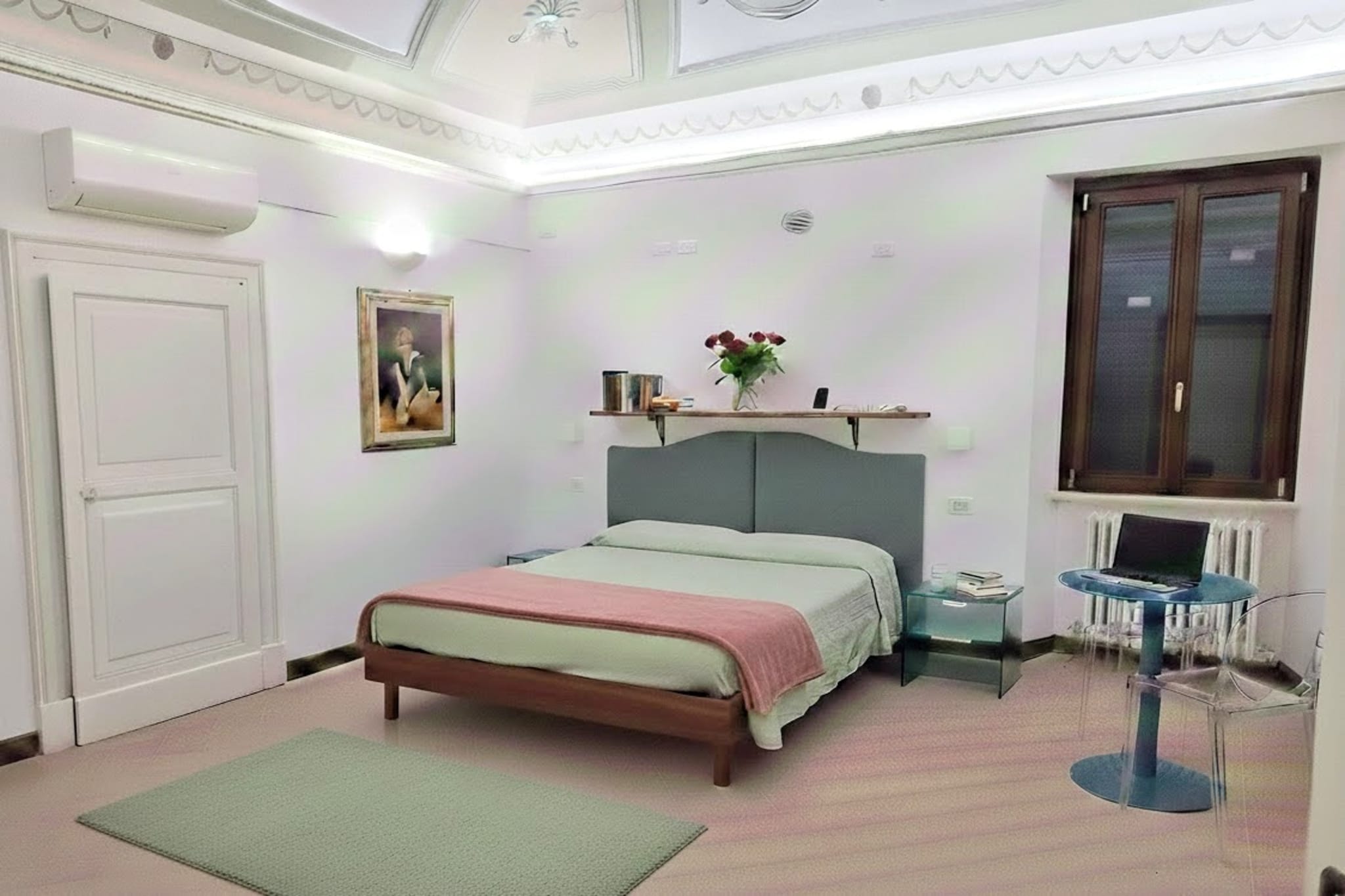 This accommodation, located in the heart of the small medieval village of Novilara, welcomes guests to brand-new apartments, recently renovated with quality materials, showcasing the historic building's charm. Some apartments retain frescoed ceilings, restored original doors, and are furnished with paintings and decorative pieces that perfectly complement the new furnishings.

All apartments are air-conditioned for maximum comfort. The property also offers a shared laundry room on the ground floor and convenient private parking just a few meters away.

At the heart of the property is an internal courtyard with a swimming pool and a relaxation area, where guests can cool off with a dip or relax on the poolside loungers. Additionally, the property offers the use of umbrellas and loungers at a beach club just a few kilometers away. Guests can book this service on-site for €15 per day for an umbrella and two loungers.

The location of these vacation homes is perfect for those seeking the tranquility of the countryside, yet just steps from the village center, where excellent restaurants await. Meanwhile, the sea and the cities of Pesaro and Fano, as well as Urbino, Senigallia, and Riccione, are easily accessible by car. Guests can also explore the beautiful surrounding hills, stroll through small villages, and discover local producers of wine, olive oil, truffles, and much more.