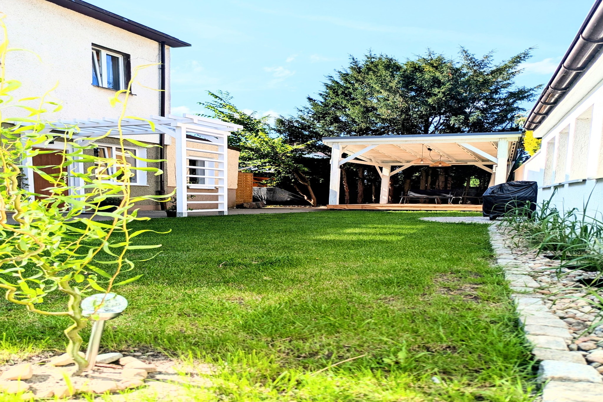 Apartament 4-osobowy na Portowej Kołobrzeg-Gardens in summer