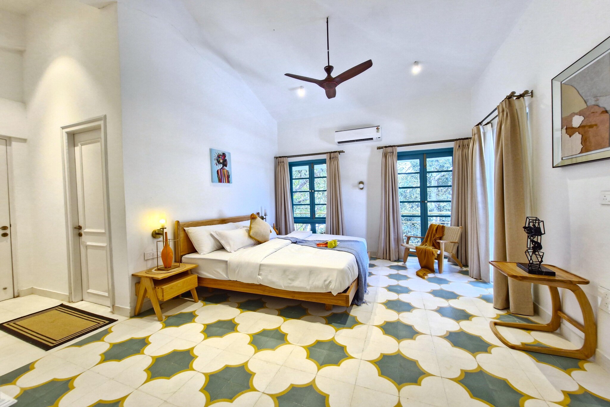 Welcome to Your Luxurious Siolim Escape-Nestled in the beauty of Siolim, Goa, our stunning 3BHK villa is your ideal escape! Experience the perfect blend of serenity and comfort in this hidden gem. Relax on beautiful beaches, indulge in delicious local cuisine, and explore the vibrant culture of this coastal paradise!
Luxurious Accommodations
Bedrooms: Each of the three spacious bedrooms features a king-sized bed and an ensuite bathroom, ensuring a restful night’s sleep.
Bedroom 1: Ground floor, garden views, easy access.
Bedroom 2 & 3: First floor with attached balconies for fresh air.
• Expansive Living Area: The heart of the villa opens out to your private pool and deck, perfect for lounging or enjoying a dip.
• Private Pool & Deck: Unwind in your own private swimming pool or soak up the sun on the spacious poolside deck, ideal for sunbathing or a quiet evening drink.
• Living Room: With views of the pool, relax with friends or family in this cozy, air-conditioned space.
• Dining Area: Gather around the dining table for meals or to play board games available in the villa.
Dining Experience
Foodies will delight in our chef-on-call service, available with 48 hours' notice, bringing delicious meals right to your table. For those who prefer a hands-on approach, the well-equipped kitchen is yours to explore.
Location & Convenience-Our villa is ideally situated close to:
• Famous Beaches: Morjim, Ashvem, Arambol, Anjuna, Baga, and Calangute beaches.
• Top Eateries: Enjoy local flavors with a variety of restaurants nearby.
• Local Attractions: Experience the vibrant culture of Goa with ease.
With daily housekeeping services, you can relax and enjoy your stay without worrying about chores.
The Perfect Getaway - Whether you're seeking a fun-filled family vacation, a romantic escape, or a serene staycation, our villa in Siolim is the ideal destination for creating unforgettable memories.
Book Your Stay Today-Get into your ideal luxurious lifestyle you deserve and experience all that Siolim has to offer!
Unmarried couples are warmly welcome at this property.
Guests with local ID proof are warmly welcome.
Apologies, but we are currently unable to host foreign nationals at this property.
Early Check-In Policy: A full day’s room rate will be charged for check-ins before 6:00 AM. Complimentary early check-in is available between 6:00 AM and 10:00 AM, subject to room availability.
Check-in is only available to guests aged 18 and above. Please provide a government-issued ID to confirm your age.